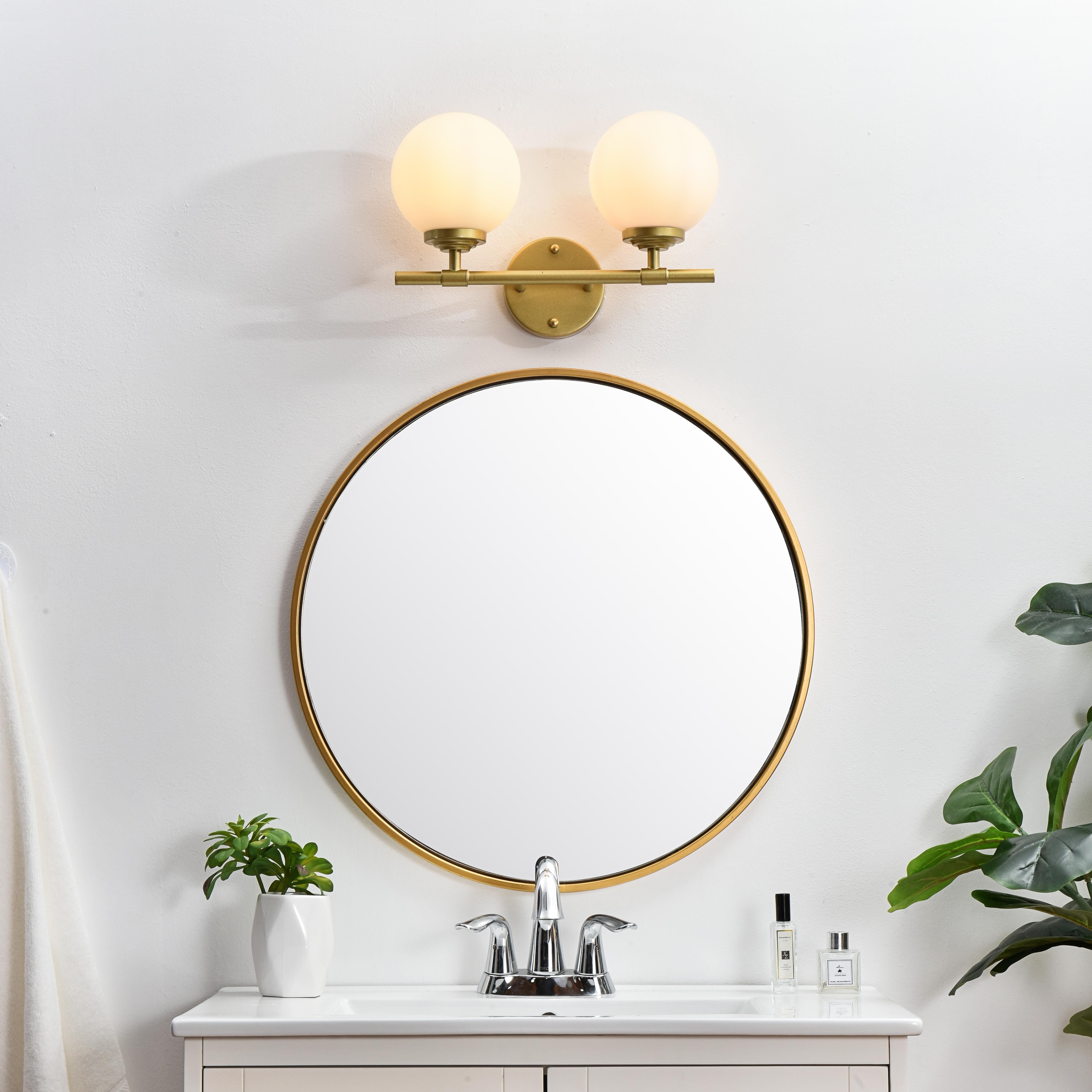 Installation Manual
Specification Sheet
Dimensions
Length: 6.9"
Width: 15"
Height: 10"
Extension: 7"
Wire Length: 8"
Depth: 7"
Specifications
Assembly Required: Yes
Bulb Included: No
#N/A
Dimmable: Yes
Distressed Finish: No
Dry/Wet/Damp: Damp
ETL: yes
Finish (Color): Brass and Frosted White
Fixture Material: Iron and Glass
Hardware Finish: Brass
Harware Material: Iron
Max/Nominal Watt: 80W
Number of Lights: 2
Product Type: Vanity Lights
Product Warranty: 1 year limited
Socket Type: E12
Voltage: 110V
Wattage/Bulb: 40W
Weight: 3
Wire Included: Yes
Shipment type: Small Parcel
US Shipping Cost: $13.00 - alternate view