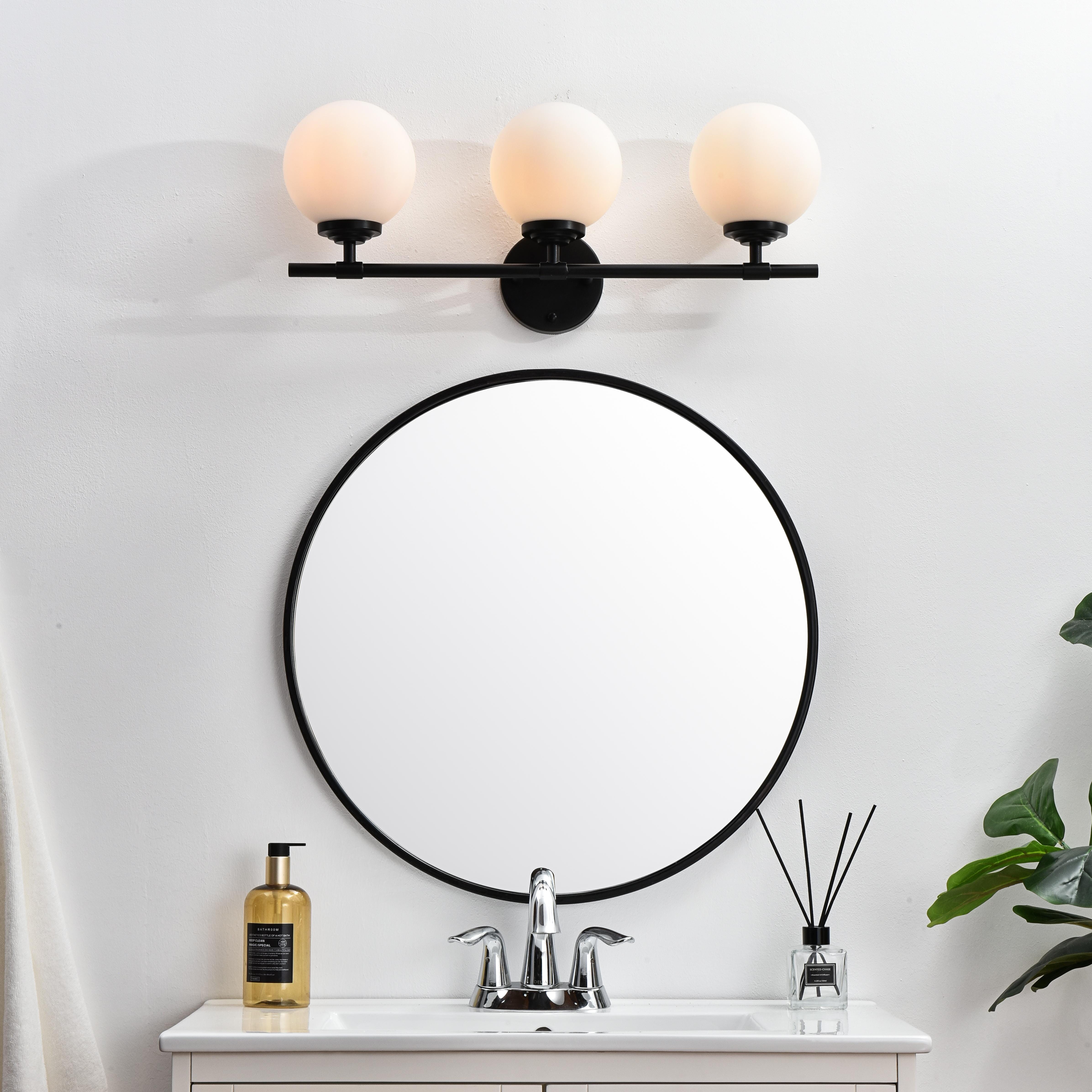 Installation Manual
Specification Sheet
Dimensions
Length: 6.9"
Width: 24"
Height: 10"
Extension: 7"
Wire Length: 8"
Depth: 7"
Specifications
Assembly Required: Yes
Bulb Included: No
#N/A
Dimmable: Yes
Distressed Finish: No
Dry/Wet/Damp: Damp
ETL: yes
Finish (Color): Black and Frosted White
Fixture Material: Iron and Glass
Hardware Finish: Black
Harware Material: Iron
Max/Nominal Watt: 120W
Number of Lights: 3
Product Type: Vanity Lights
Product Warranty: 1 year limited
Socket Type: E12
Voltage: 110V
Wattage/Bulb: 40W
Weight: 4
Wire Included: Yes
Shipment type: Small Parcel
US Shipping Cost: $14.00 - alternate view