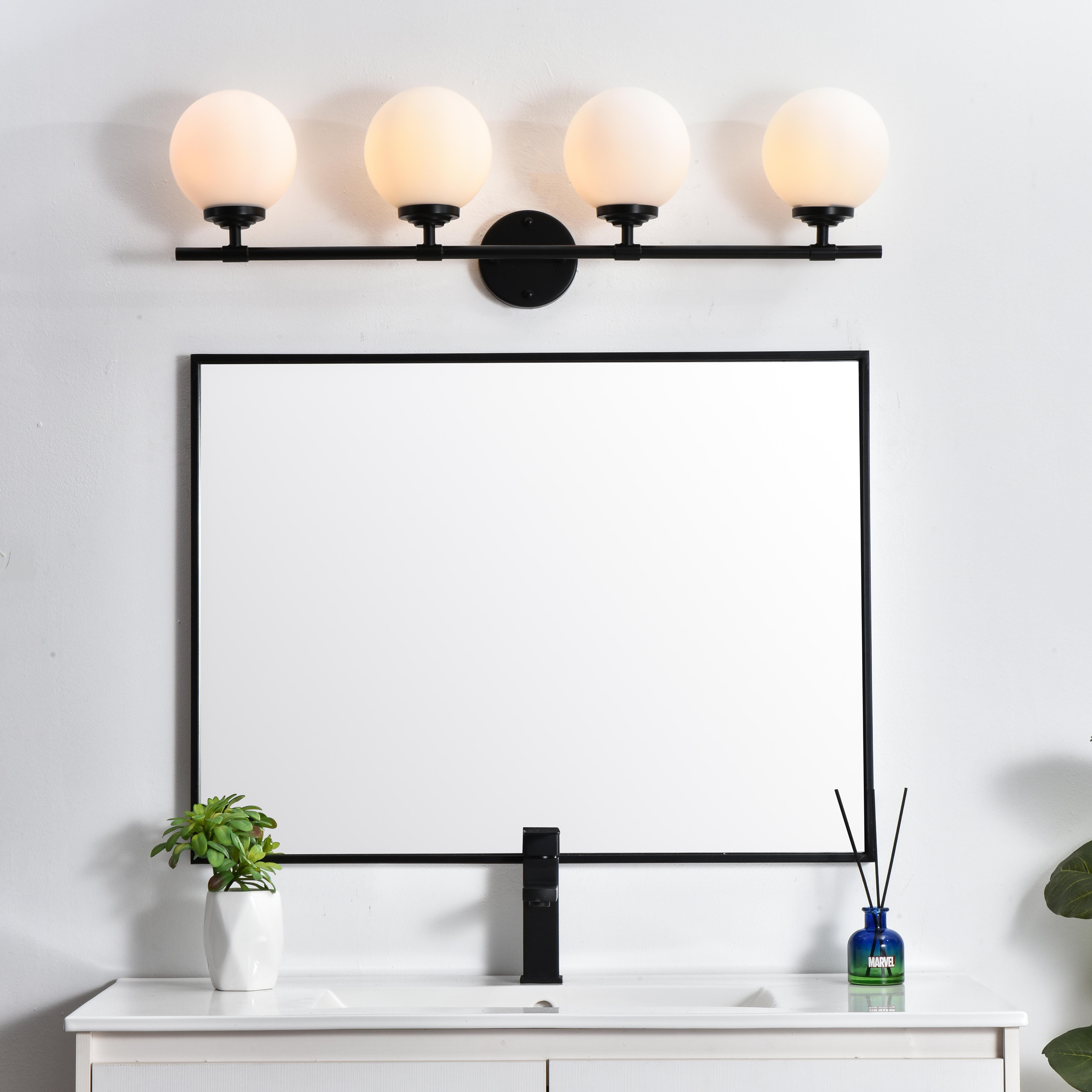 Installation Manual
Specification Sheet
Dimensions
Length: 6.9"
Width: 33"
Height: 10"
Extension: 7"
Wire Length: 8"
Depth: 7"
Specifications
Assembly Required: Yes
Bulb Included: No
#N/A
Dimmable: Yes
Distressed Finish: No
Dry/Wet/Damp: Damp
ETL: yes
Finish (Color): Black and Frosted White
Fixture Material: Iron and Glass
Hardware Finish: Black
Harware Material: Iron
Max/Nominal Watt: 160W
Number of Lights: 4
Product Type: Vanity Lights
Product Warranty: 1 year limited
Socket Type: E12
Voltage: 110V
Wattage/Bulb: 40W
Weight: 5
Wire Included: Yes
Shipment type: Small Parcel
US Shipping Cost: $17.00 - alternate view