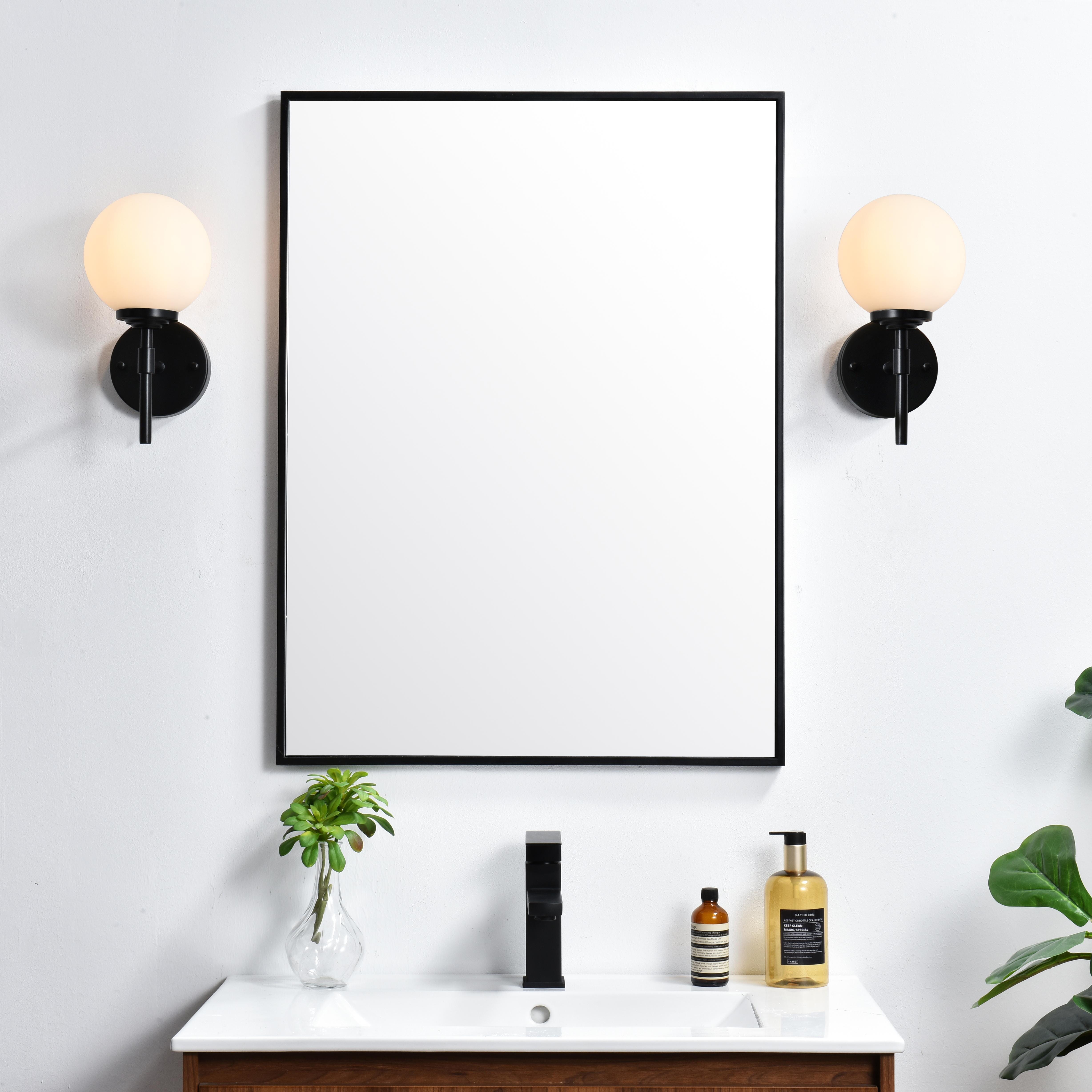 Installation Manual
Specification Sheet
Dimensions
Length: 6.9"
Width: 6"
Height: 12"
Extension: 7"
Wire Length: 8"
Depth: 7"
Specifications
Assembly Required: Yes
Bulb Included: No
#N/A
Dimmable: Yes
Distressed Finish: No
Dry/Wet/Damp: Damp
ETL: yes
Finish (Color): Black and Frosted White
Fixture Material: Iron and Glass
Hardware Finish: Black
Harware Material: Iron
Max/Nominal Watt: 40W
Number of Lights: 1
Product Type: Vanity Lights
Product Warranty: 1 year limited
Socket Type: E12
Voltage: 110V
Wattage/Bulb: 40W
Weight: 2
Wire Included: Yes
Shipment type: Small Parcel
US Shipping Cost: $13.00 - alternate view