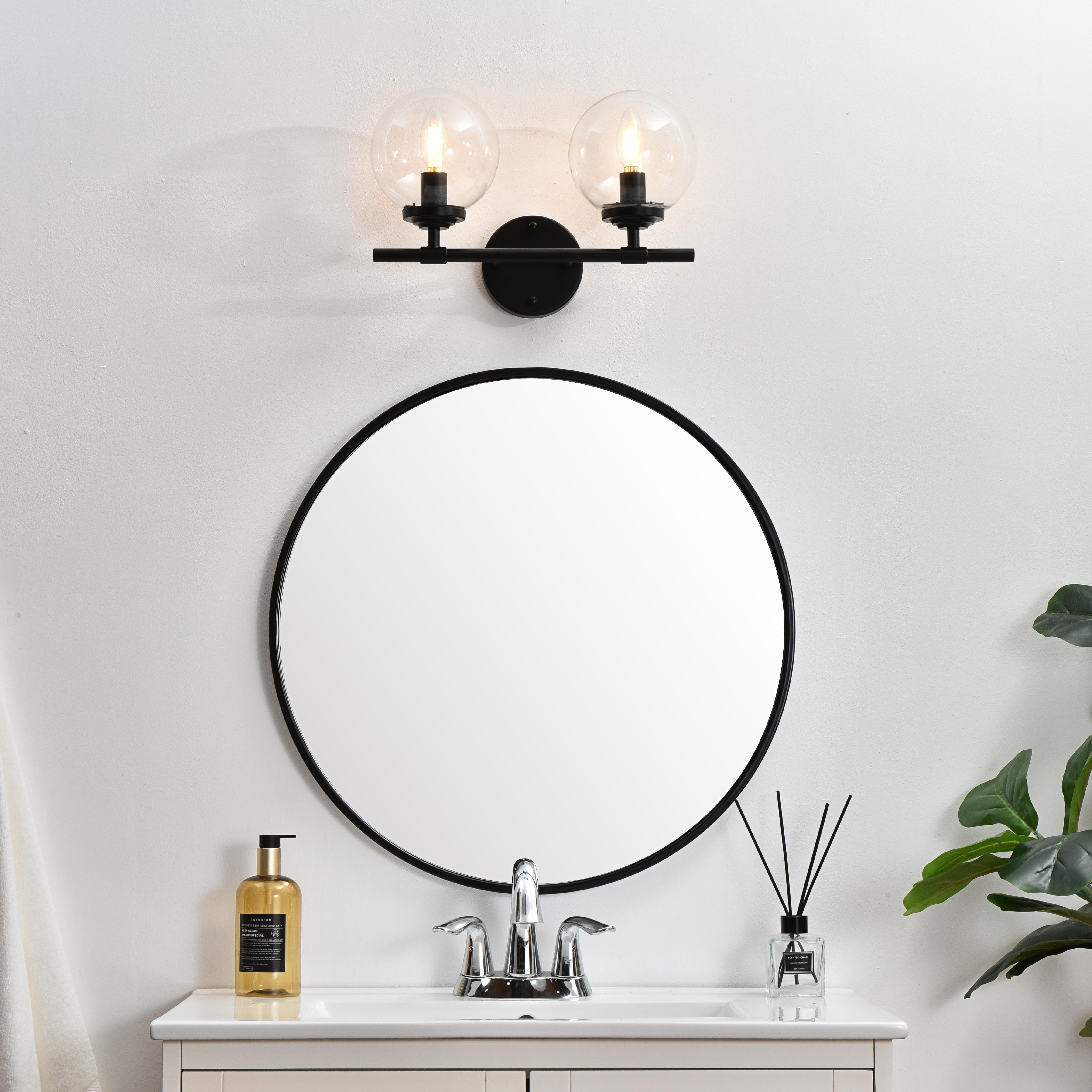 Installation Manual
Specification Sheet
Dimensions
Length: 6.9"
Width: 15"
Height: 10"
Extension: 7"
Wire Length: 8"
Depth: 7"
Specifications
Assembly Required: Yes
Bulb Included: No
#N/A
Dimmable: Yes
Distressed Finish: No
Dry/Wet/Damp: Damp
ETL: yes
Finish (Color): Black and Clear
Fixture Material: Iron and Glass
Hardware Finish: Black
Harware Material: Iron
Max/Nominal Watt: 80W
Number of Lights: 2
Product Type: Vanity Lights
Product Warranty: 1 year limited
Socket Type: E12
Voltage: 110V
Wattage/Bulb: 40W
Weight: 3
Wire Included: Yes
Shipment type: Small Parcel
US Shipping Cost: $13.00 - alternate view