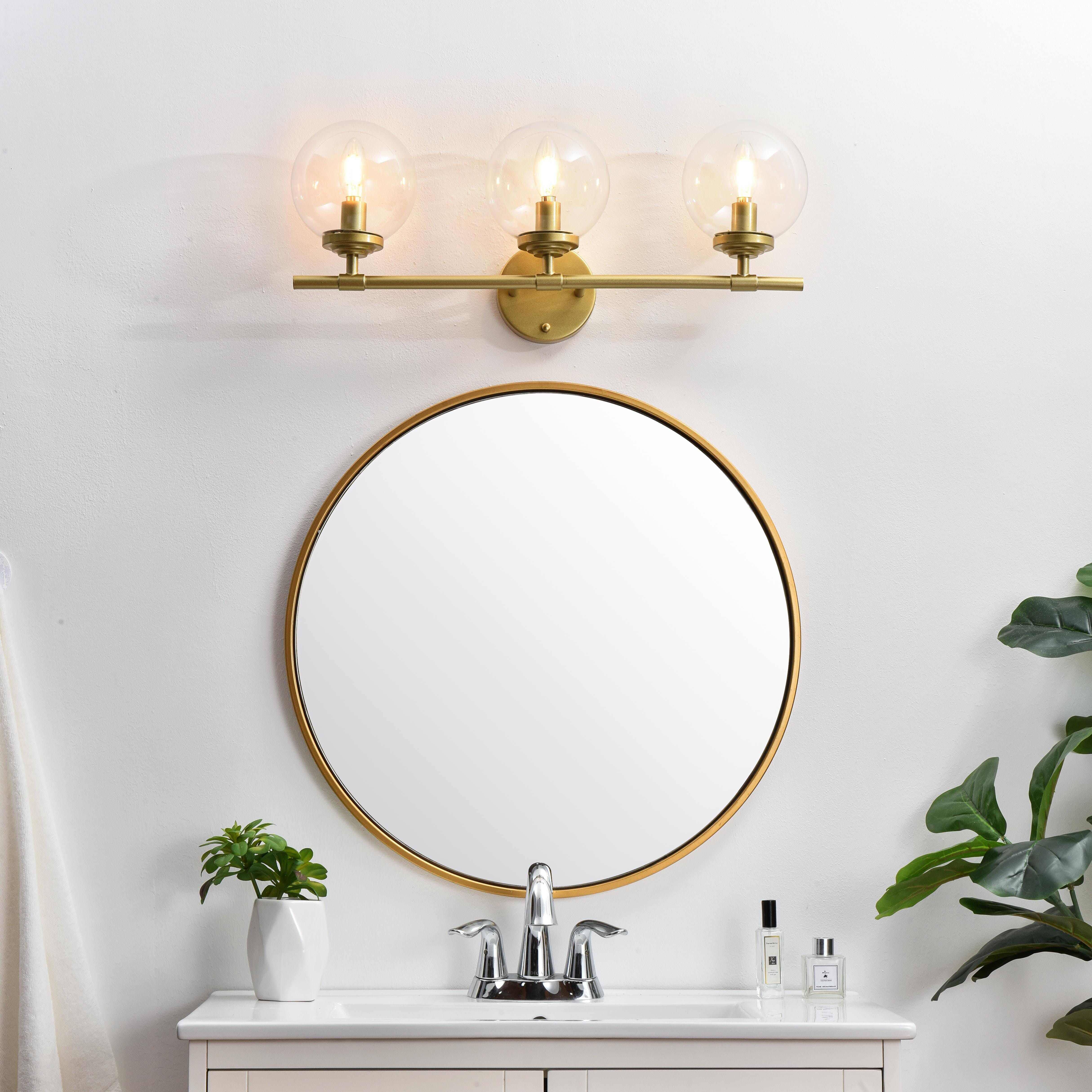 Installation Manual
Specification Sheet
Dimensions
Length: 6.9"
Width: 24"
Height: 10"
Extension: 7"
Wire Length: 8"
Depth: 7"
Specifications
Assembly Required: Yes
Bulb Included: No
#N/A
Dimmable: Yes
Distressed Finish: No
Dry/Wet/Damp: Damp
ETL: yes
Finish (Color): Brass and Clear
Fixture Material: Iron and Glass
Hardware Finish: Brass
Harware Material: Iron
Max/Nominal Watt: 120W
Number of Lights: 3
Product Type: Vanity Lights
Product Warranty: 1 year limited
Socket Type: E12
Voltage: 110V
Wattage/Bulb: 40W
Weight: 4
Wire Included: Yes
Shipment type: Small Parcel
US Shipping Cost: $14.00 - alternate view