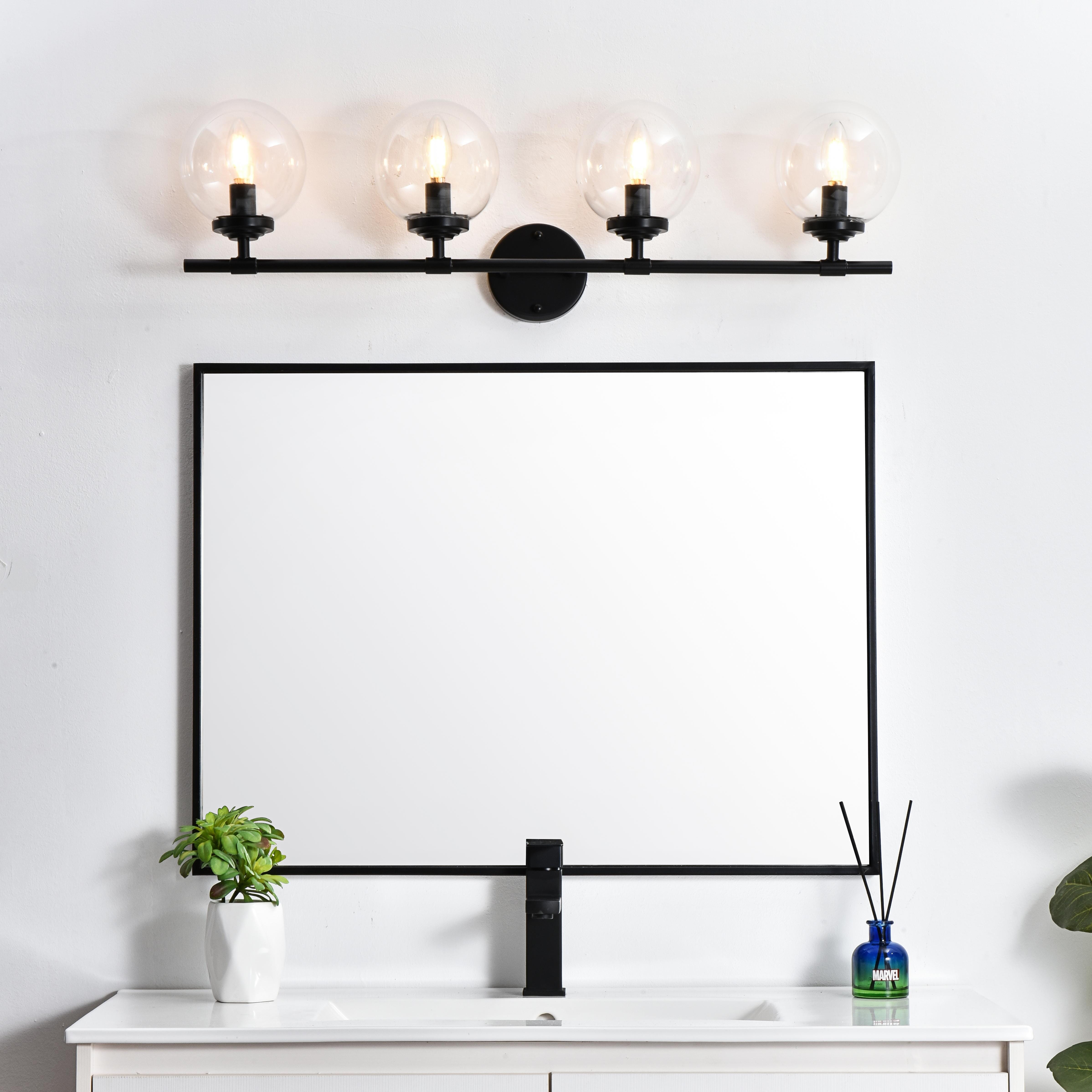 Installation Manual
Specification Sheet
Dimensions
Length: 6.9"
Width: 33"
Height: 10"
Extension: 7"
Wire Length: 8"
Depth: 7"
Specifications
Assembly Required: Yes
Bulb Included: No
#N/A
Dimmable: Yes
Distressed Finish: No
Dry/Wet/Damp: Damp
ETL: yes
Finish (Color): Black and Clear
Fixture Material: Iron and Glass
Hardware Finish: Black
Harware Material: Iron
Max/Nominal Watt: 160W
Number of Lights: 4
Product Type: Vanity Lights
Product Warranty: 1 year limited
Socket Type: E12
Voltage: 110V
Wattage/Bulb: 40W
Weight: 5
Wire Included: Yes
Shipment type: Small Parcel
US Shipping Cost: $17.00 - alternate view