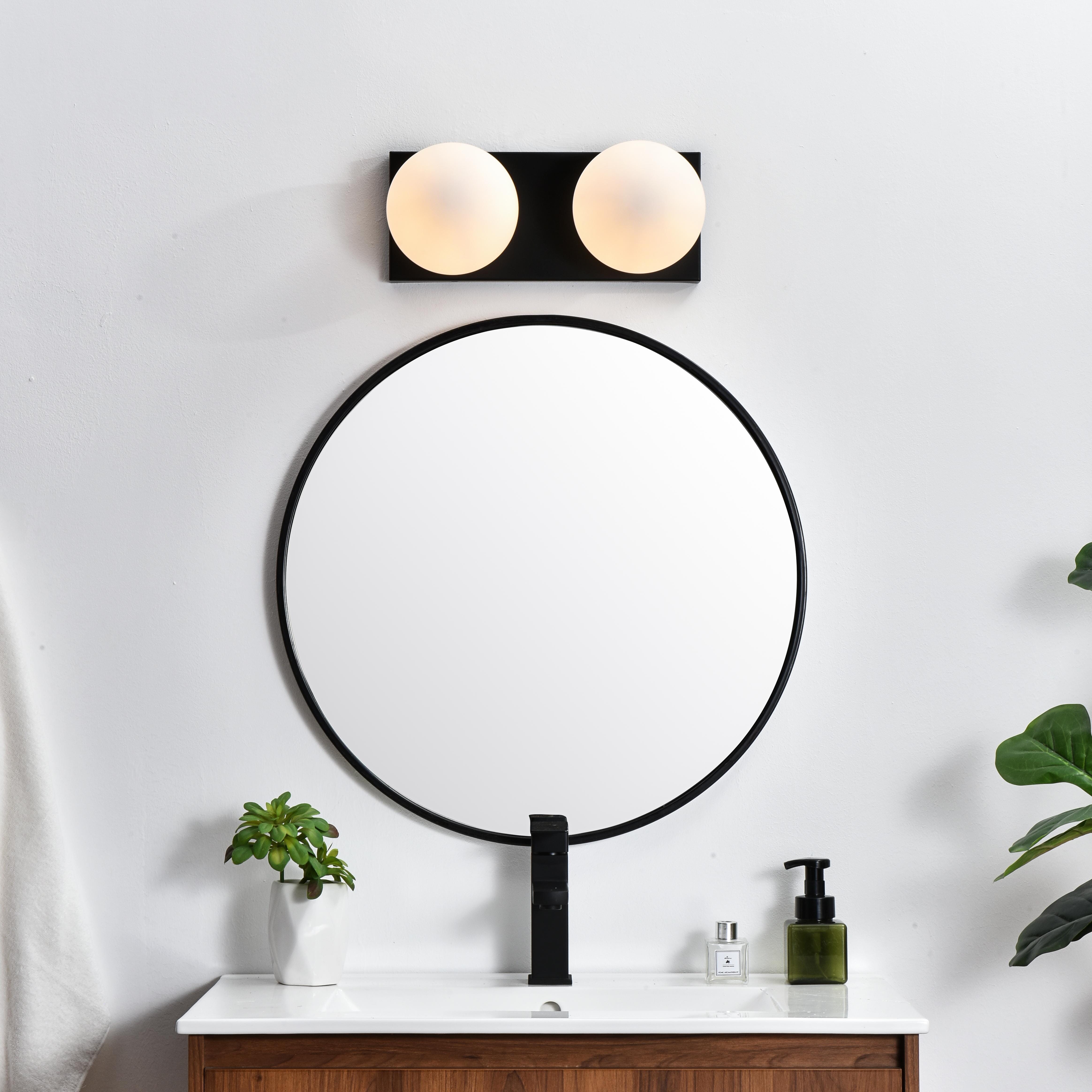 Installation Manual
Specification Sheet
Dimensions
Length: 6.9"
Width: 14"
Height: 6"
Extension: 7"
Wire Length: 8"
Depth: 7"
Specifications
Assembly Required: Yes
Bulb Included: No
#N/A
Dimmable: Yes
Distressed Finish: No
Dry/Wet/Damp: Damp
ETL: yes
Finish (Color): Black and Frosted White
Fixture Material: Iron and Glass
Hardware Finish: Black
Harware Material: Iron
Max/Nominal Watt: 80W
Number of Lights: 2
Product Type: Vanity Lights
Product Warranty: 1 year limited
Socket Type: E12
Voltage: 110V
Wattage/Bulb: 40W
Weight: 4
Wire Included: Yes
Shipment type: Small Parcel
US Shipping Cost: $13.00 - alternate view