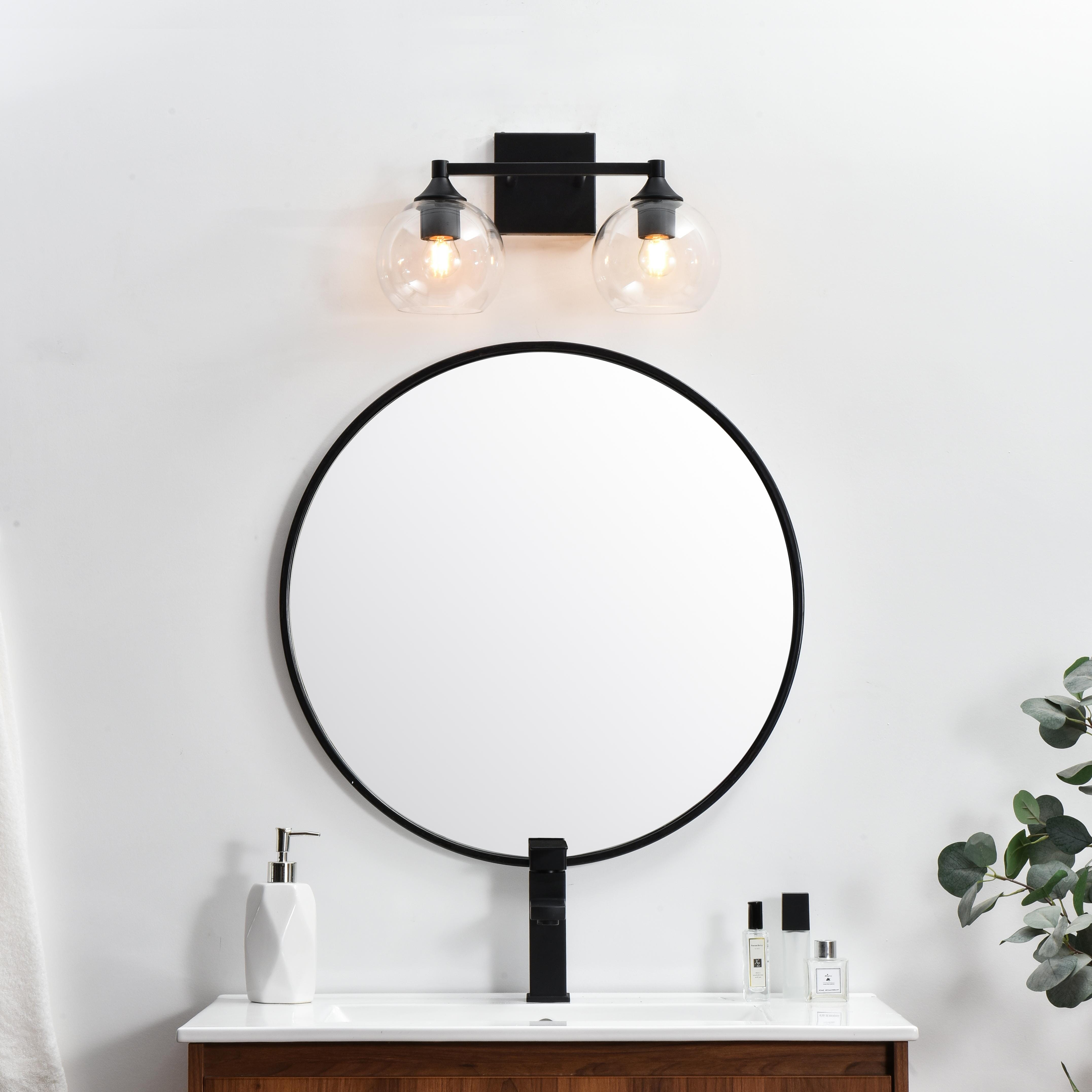 Specification Sheet
Dimensions
Length: 7.6"
Width: 16"
Height: 9"
Extension: 8"
Wire Length: 8"
Depth: 8"
Specifications
Assembly Required: Yes
Bulb Included: No
#N/A
Dimmable: Yes
Distressed Finish: No
Dry/Wet/Damp: Damp
ETL: yes
Finish (Color): Black and Clear
Fixture Material: Iron and Glass
Hardware Finish: Black
Harware Material: Iron
Max/Nominal Watt: 80W
Number of Lights: 2
Product Type: Vanity Lights
Product Warranty: 1 year limited
Socket Type: E26
Voltage: 110V
Wattage/Bulb: 40W
Weight: 3
Wire Included: Yes
Shipment type: Small Parcel
US Shipping Cost: $13.00 - alternate view