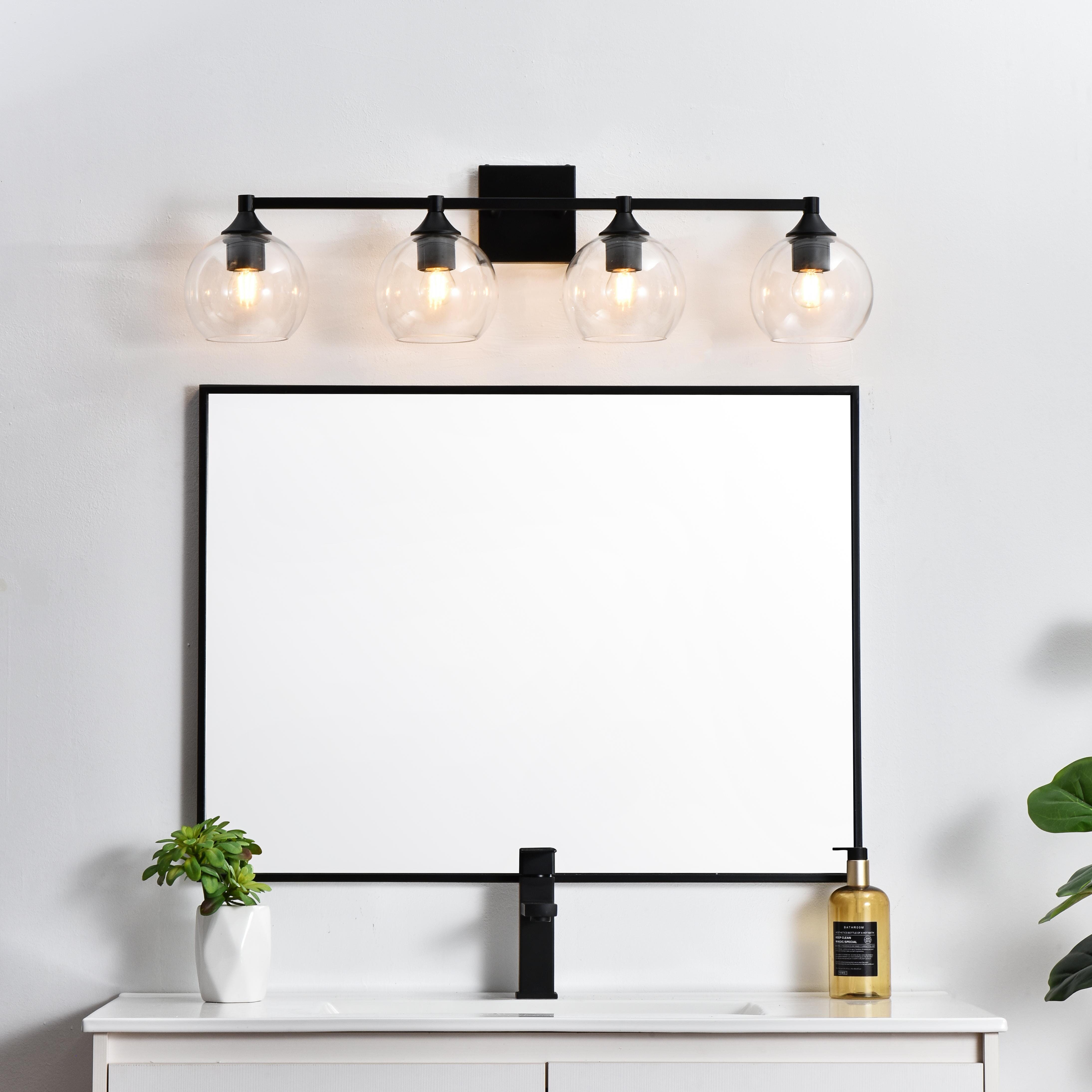 Specification Sheet
Dimensions
Length: 7.6"
Width: 33"
Height: 9"
Extension: 8"
Wire Length: 8"
Depth: 8"
Specifications
Assembly Required: Yes
Bulb Included: No
#N/A
Dimmable: Yes
Distressed Finish: No
Dry/Wet/Damp: Damp
ETL: yes
Finish (Color): Black and Clear
Fixture Material: Iron and Glass
Hardware Finish: Black
Harware Material: Iron
Max/Nominal Watt: 160W
Number of Lights: 4
Product Type: Vanity Lights
Product Warranty: 1 year limited
Socket Type: E26
Voltage: 110V
Wattage/Bulb: 40W
Weight: 5
Wire Included: Yes
Shipment type: Small Parcel
US Shipping Cost: $14.00 - alternate view