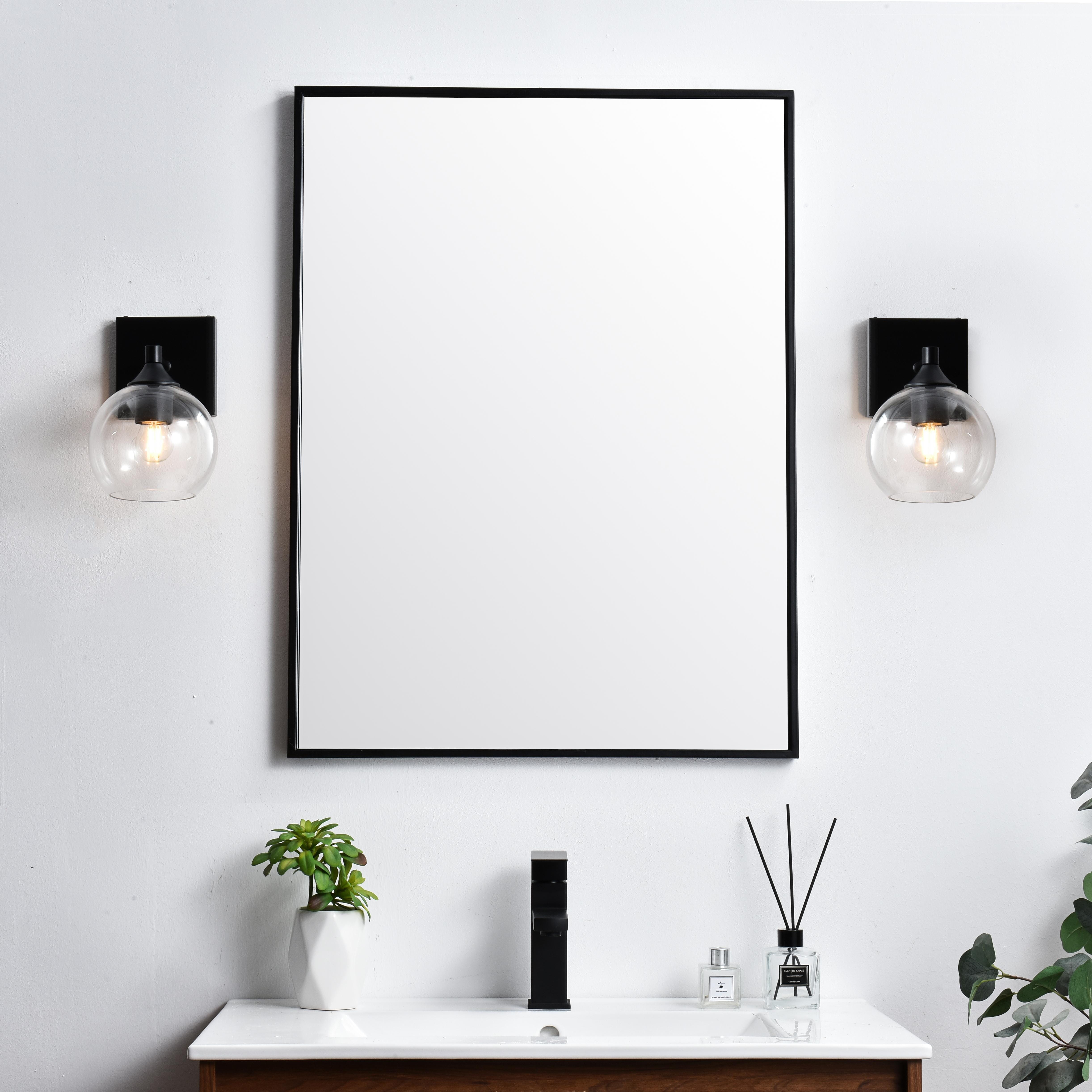 Specification Sheet
Dimensions
Length: 7.6"
Width: 6"
Height: 9"
Extension: 8"
Wire Length: 8"
Depth: 8"
Specifications
Assembly Required: Yes
Bulb Included: No
#N/A
Dimmable: Yes
Distressed Finish: No
Dry/Wet/Damp: Damp
ETL: yes
Finish (Color): Black and Clear
Fixture Material: Iron and Glass
Hardware Finish: Black
Harware Material: Iron
Max/Nominal Watt: 40W
Number of Lights: 1
Product Type: Vanity Lights
Product Warranty: 1 year limited
Socket Type: E26
Voltage: 110V
Wattage/Bulb: 40W
Weight: 2
Wire Included: Yes
Shipment type: Small Parcel
US Shipping Cost: $13.00 - alternate view