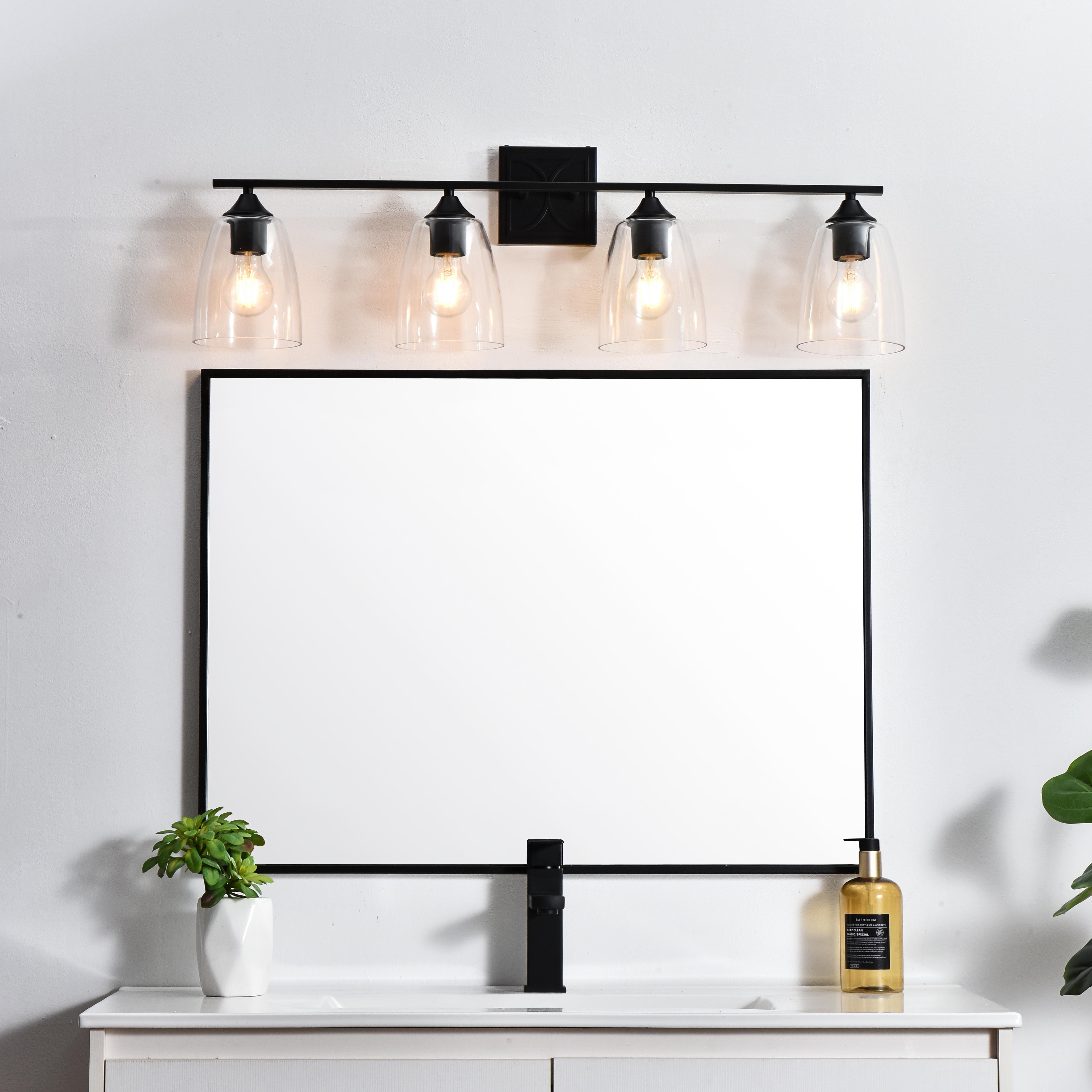 Specification Sheet
Dimensions
Length: 6.5"
Width: 34"
Height: 10"
Extension: 6.5"
Wire Length: 8"
Depth: 6.5"
Specifications
Assembly Required: Yes
Bulb Included: No
#N/A
Dimmable: Yes
Distressed Finish: No
Dry/Wet/Damp: Damp
ETL: yes
Finish (Color): Black and Clear
Fixture Material: Iron and Glass
Hardware Finish: Black
Harware Material: Iron
Max/Nominal Watt: 160W
Number of Lights: 4
Product Type: Vanity Lights
Product Warranty: 1 year limited
Socket Type: E26
Voltage: 110V
Wattage/Bulb: 40W
Weight: 6
Wire Included: Yes
Shipment type: Small Parcel
US Shipping Cost: $16.00 - alternate view