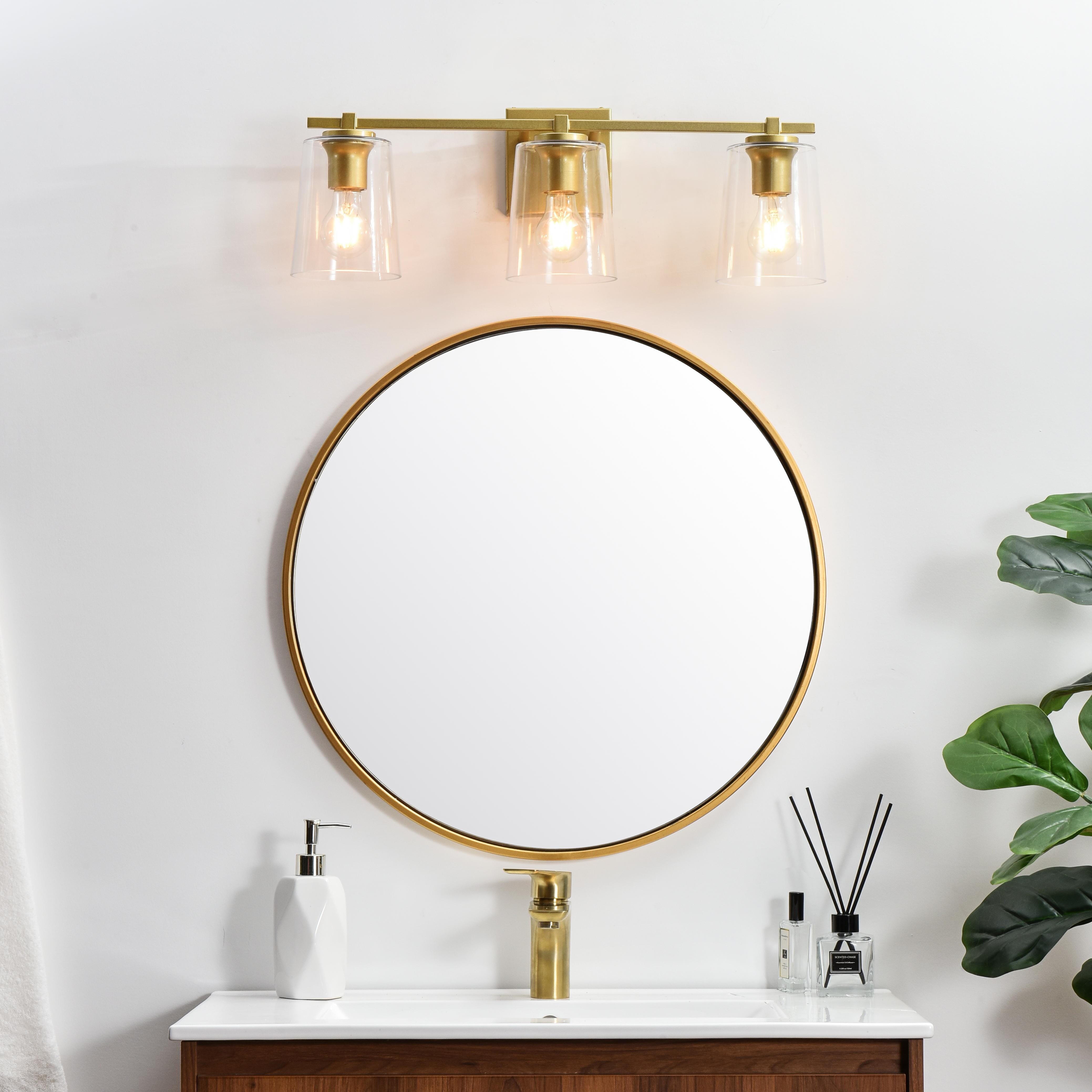 Specification Sheet
Dimensions
Length: 7.4"
Width: 23"
Height: 8"
Extension: 7"
Wire Length: 8"
Depth: 7"
Specifications
Assembly Required: Yes
Bulb Included: No
#N/A
Dimmable: Yes
Distressed Finish: No
Dry/Wet/Damp: Damp
ETL: yes
Finish (Color): Brass and Clear
Fixture Material: Iron and Glass
Hardware Finish: Brass
Harware Material: Iron
Max/Nominal Watt: 120W
Number of Lights: 3
Product Type: Vanity Lights
Product Warranty: 1 year limited
Socket Type: E26
Voltage: 110V
Wattage/Bulb: 40W
Weight: 5
Wire Included: Yes
Shipment type: Small Parcel
US Shipping Cost: $13.00 - alternate view