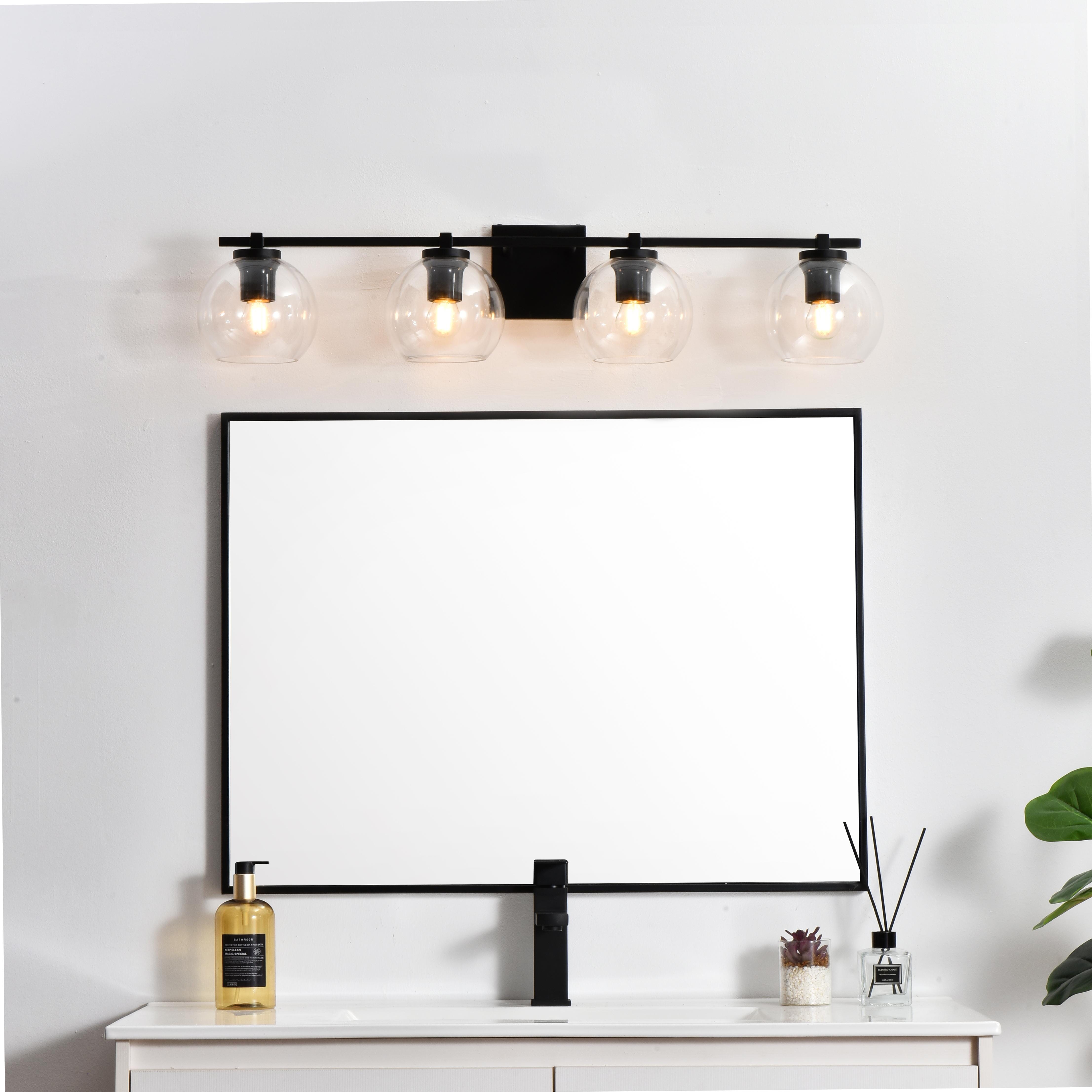 Specification Sheet
Dimensions
Length: 7.9"
Width: 34"
Height: 7"
Extension: 8"
Wire Length: 8"
Depth: 8"
Specifications
Assembly Required: Yes
Bulb Included: No
#N/A
Dimmable: Yes
Distressed Finish: No
Dry/Wet/Damp: Damp
ETL: yes
Finish (Color): Black and Clear
Fixture Material: Iron and Glass
Hardware Finish: Black
Harware Material: Iron
Max/Nominal Watt: 160W
Number of Lights: 4
Product Type: Vanity Lights
Product Warranty: 1 year limited
Socket Type: E26
Voltage: 110V
Wattage/Bulb: 40W
Weight: 5
Wire Included: Yes
Shipment type: Small Parcel
US Shipping Cost: $16.00 - alternate view