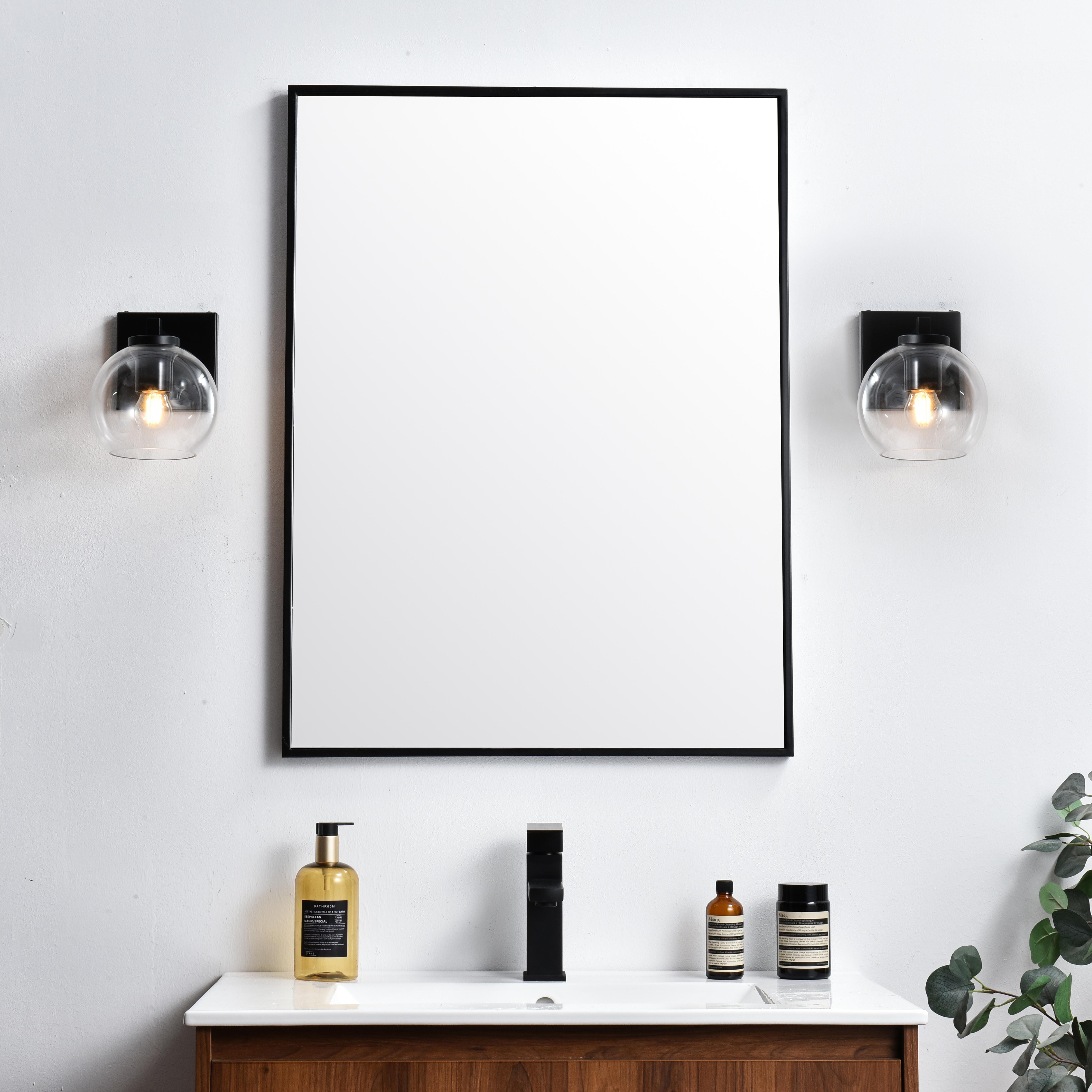 Specification Sheet
Dimensions
Length: 7.9"
Width: 6"
Height: 7"
Extension: 8"
Wire Length: 8"
Depth: 8"
Specifications
Assembly Required: Yes
Bulb Included: No
#N/A
Dimmable: Yes
Distressed Finish: No
Dry/Wet/Damp: Damp
ETL: yes
Finish (Color): Black and Clear
Fixture Material: Iron and Glass
Hardware Finish: Black
Harware Material: Iron
Max/Nominal Watt: 40W
Number of Lights: 1
Product Type: Vanity Lights
Product Warranty: 1 year limited
Socket Type: E26
Voltage: 110V
Wattage/Bulb: 40W
Weight: 2
Wire Included: Yes
Shipment type: Small Parcel
US Shipping Cost: $13.00 - alternate view