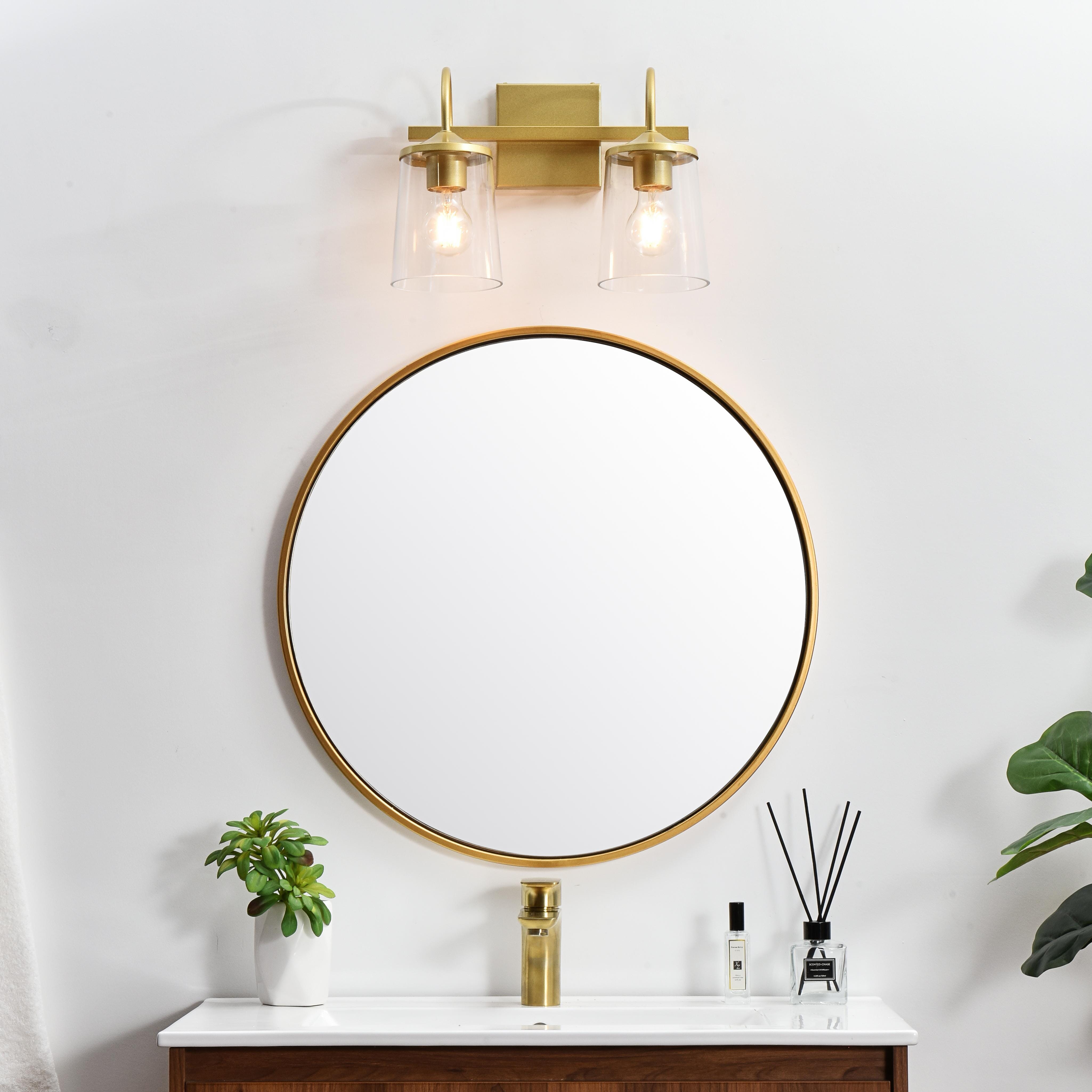 Specification Sheet
Dimensions
Length: 8.1"
Width: 14"
Height: 10"
Extension: 8"
Wire Length: 8"
Depth: 8"
Specifications
Assembly Required: Yes
Bulb Included: No
#N/A
Dimmable: Yes
Distressed Finish: No
Dry/Wet/Damp: Damp
ETL: yes
Finish (Color): Brass and Clear
Fixture Material: Iron and Glass
Hardware Finish: Brass
Harware Material: Iron
Max/Nominal Watt: 80W
Number of Lights: 2
Product Type: Vanity Lights
Product Warranty: 1 year limited
Socket Type: E26
Voltage: 110V
Wattage/Bulb: 40W
Weight: 4
Wire Included: Yes
Shipment type: Small Parcel
US Shipping Cost: $13.00 - alternate view