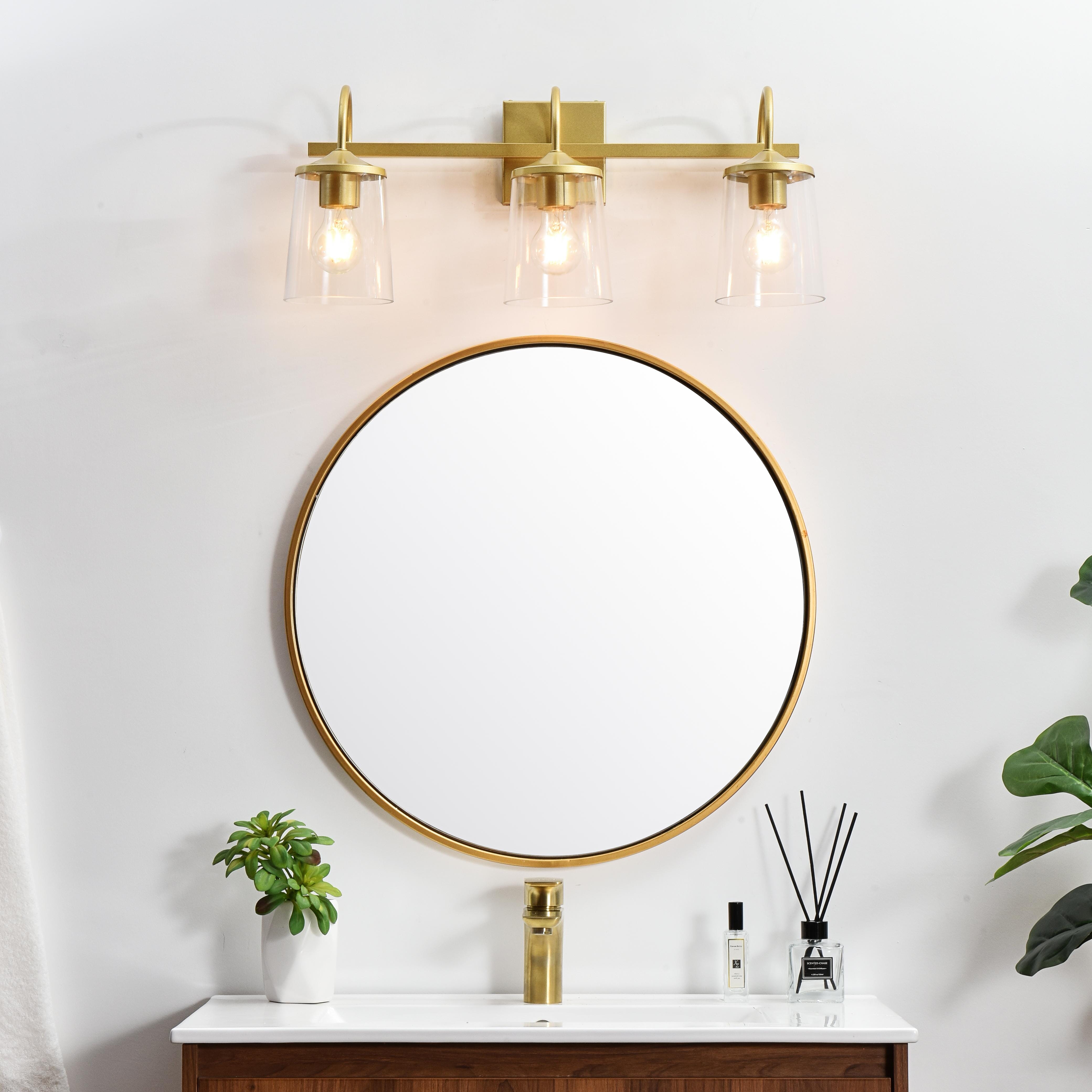 Specification Sheet
Dimensions
Length: 8.1"
Width: 24"
Height: 10"
Extension: 8"
Wire Length: 8"
Depth: 8"
Specifications
Assembly Required: Yes
Bulb Included: No
#N/A
Dimmable: Yes
Distressed Finish: No
Dry/Wet/Damp: Damp
ETL: yes
Finish (Color): Brass and Clear
Fixture Material: Iron and Glass
Hardware Finish: Brass
Harware Material: Iron
Max/Nominal Watt: 120W
Number of Lights: 3
Product Type: Vanity Lights
Product Warranty: 1 year limited
Socket Type: E26
Voltage: 110V
Wattage/Bulb: 40W
Weight: 5
Wire Included: Yes
Shipment type: Small Parcel
US Shipping Cost: $14.00 - alternate view