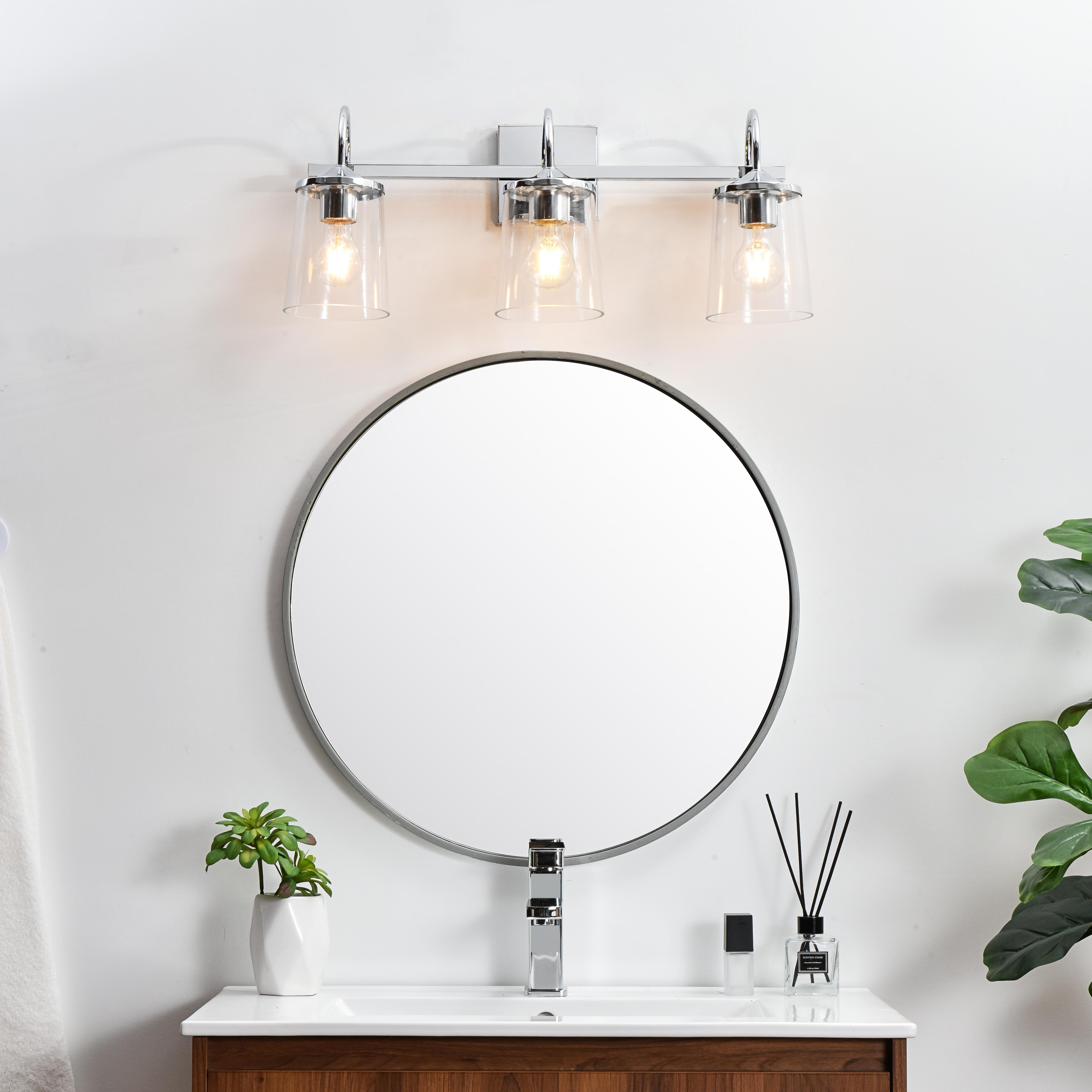 Specification Sheet
Dimensions
Length: 8.1"
Width: 24"
Height: 10"
Extension: 8"
Wire Length: 8"
Depth: 8"
Specifications
Assembly Required: Yes
Bulb Included: No
#N/A
Dimmable: Yes
Distressed Finish: No
Dry/Wet/Damp: Damp
ETL: yes
Finish (Color): Chrome and Clear
Fixture Material: Iron and Glass
Hardware Finish: Chrome
Harware Material: Iron
Max/Nominal Watt: 120W
Number of Lights: 3
Product Type: Vanity Lights
Product Warranty: 1 year limited
Socket Type: E26
Voltage: 110V
Wattage/Bulb: 40W
Weight: 5
Wire Included: Yes
Shipment type: Small Parcel
US Shipping Cost: $14.00 - alternate view