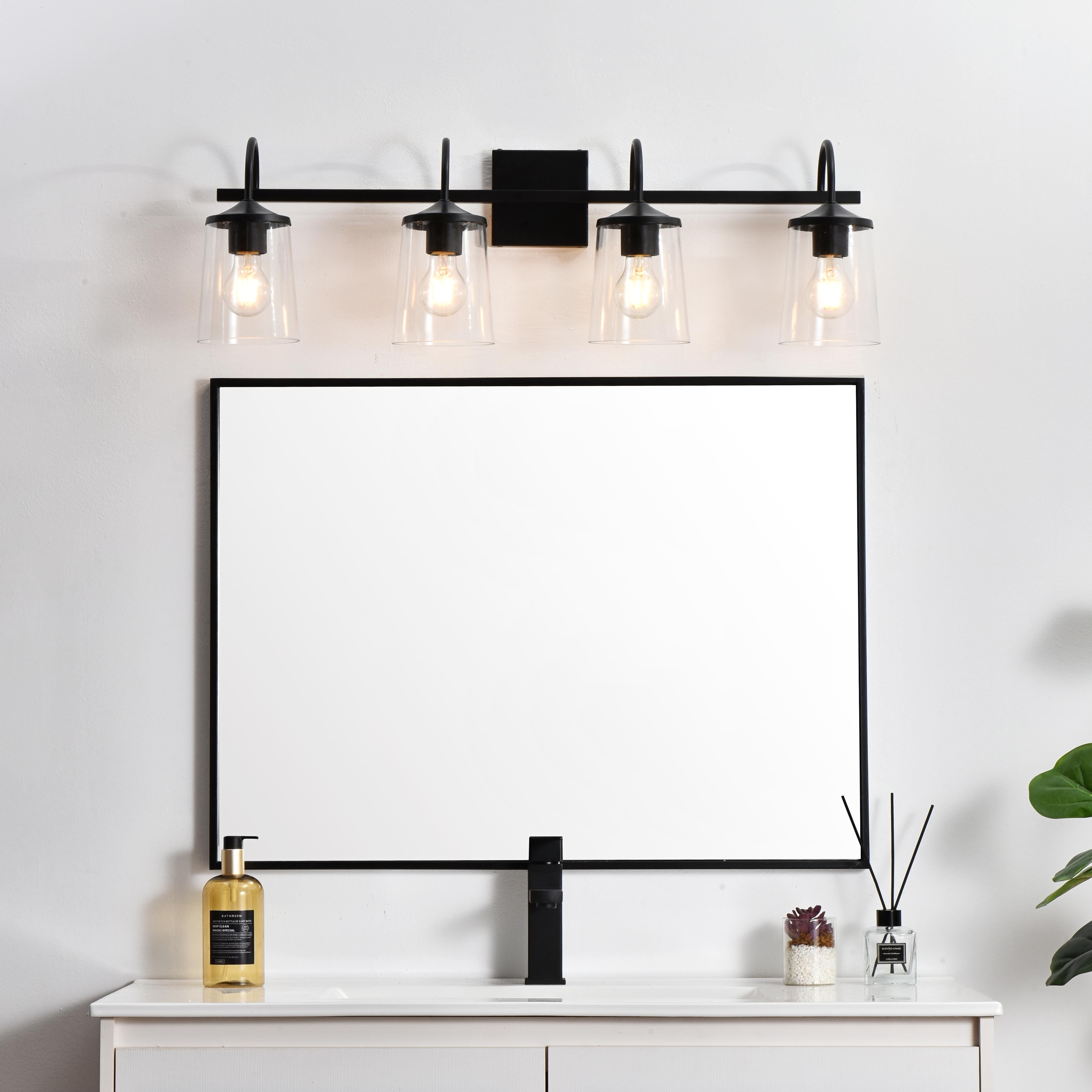 Specification Sheet
Dimensions
Length: 8.1"
Width: 33"
Height: 10"
Extension: 8"
Wire Length: 8"
Depth: 8"
Specifications
Assembly Required: Yes
Bulb Included: No
#N/A
Dimmable: Yes
Distressed Finish: No
Dry/Wet/Damp: Damp
ETL: yes
Finish (Color): Black and Clear
Fixture Material: Iron and Glass
Hardware Finish: Black
Harware Material: Iron
Max/Nominal Watt: 160W
Number of Lights: 4
Product Type: Vanity Lights
Product Warranty: 1 year limited
Socket Type: E26
Voltage: 110V
Wattage/Bulb: 40W
Weight: 7
Wire Included: Yes
Shipment type: Small Parcel
US Shipping Cost: $17.00 - alternate view