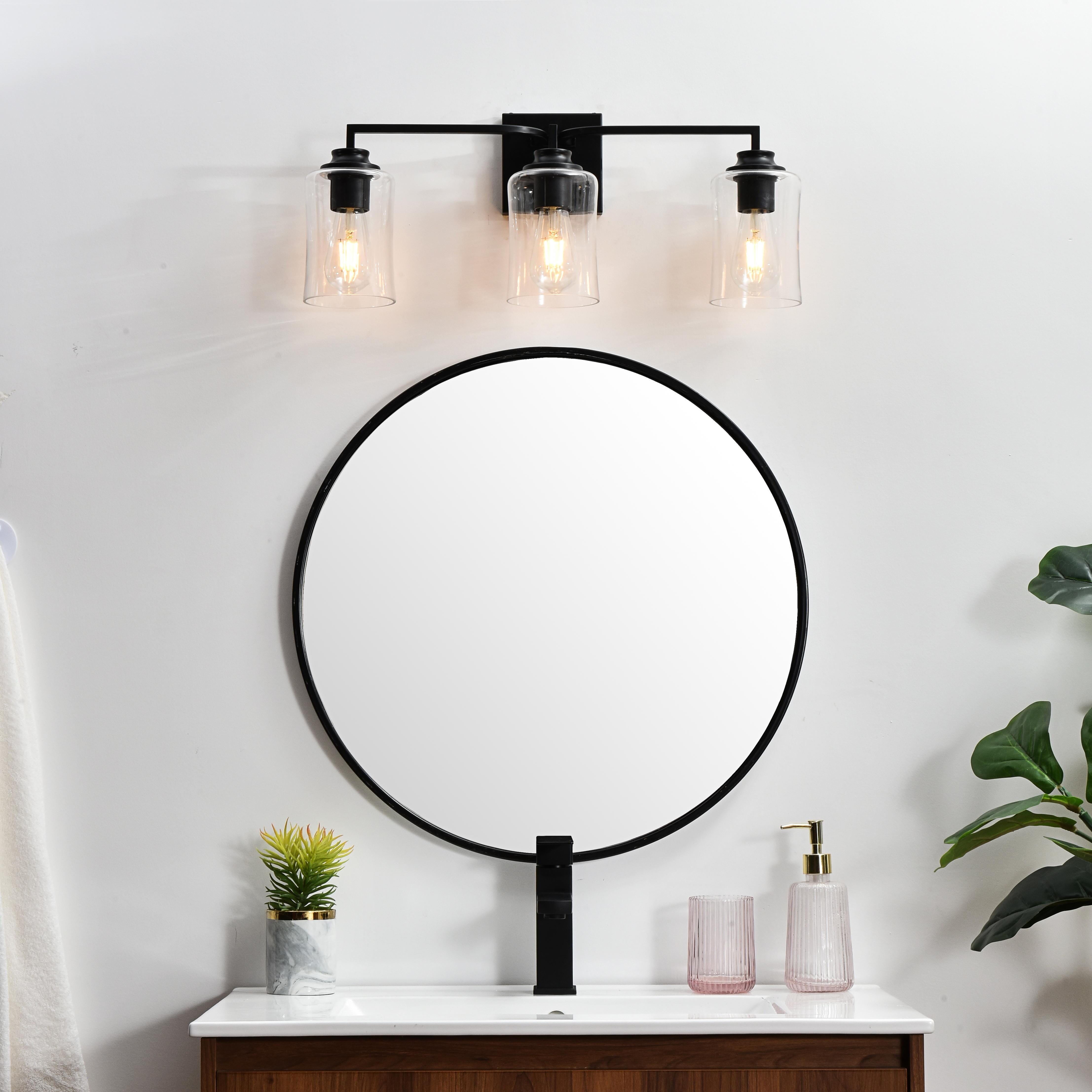 Specification Sheet
Dimensions
Length: 6"
Width: 23"
Height: 9"
Extension: 6"
Wire Length: 8"
Depth: 6"
Specifications
Assembly Required: Yes
Bulb Included: No
#N/A
Dimmable: Yes
Distressed Finish: No
Dry/Wet/Damp: Damp
ETL: yes
Finish (Color): Black and Clear
Fixture Material: Iron and Glass
Hardware Finish: Black
Harware Material: Iron
Max/Nominal Watt: 120W
Number of Lights: 3
Product Type: Vanity Lights
Product Warranty: 1 year limited
Socket Type: E26
Voltage: 110V
Wattage/Bulb: 40W
Weight: 4
Wire Included: Yes
Shipment type: Small Parcel
US Shipping Cost: $13.00 - alternate view