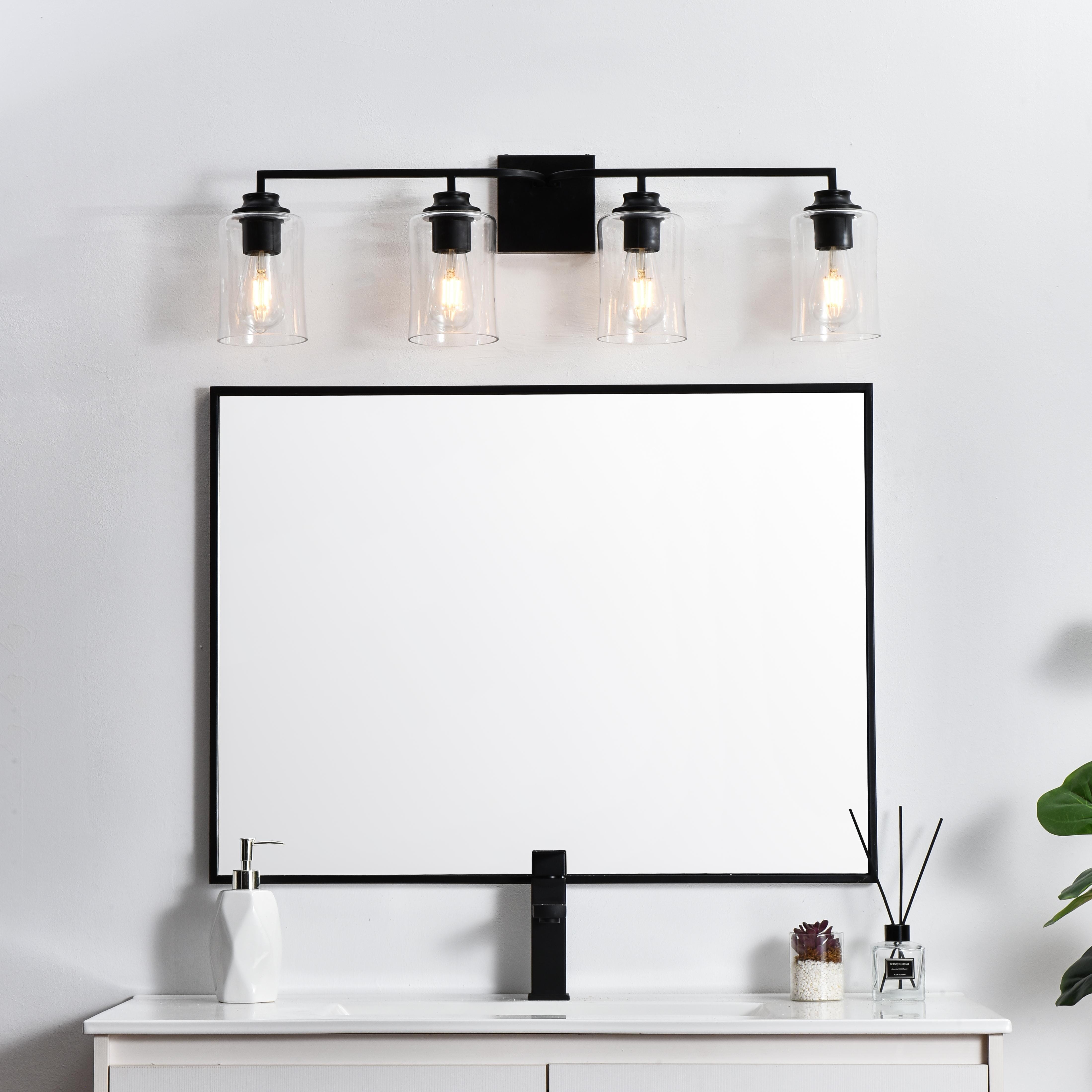 Specification Sheet
Dimensions
Length: 6"
Width: 32"
Height: 9"
Extension: 6"
Wire Length: 8"
Depth: 6"
Specifications
Assembly Required: Yes
Bulb Included: No
#N/A
Dimmable: Yes
Distressed Finish: No
Dry/Wet/Damp: Damp
ETL: yes
Finish (Color): Black and Clear
Fixture Material: Iron and Glass
Hardware Finish: Black
Harware Material: Iron
Max/Nominal Watt: 160W
Number of Lights: 4
Product Type: Vanity Lights
Product Warranty: 1 year limited
Socket Type: E26
Voltage: 110V
Wattage/Bulb: 40W
Weight: 6
Wire Included: Yes
Shipment type: Small Parcel
US Shipping Cost: $13.00 - alternate view