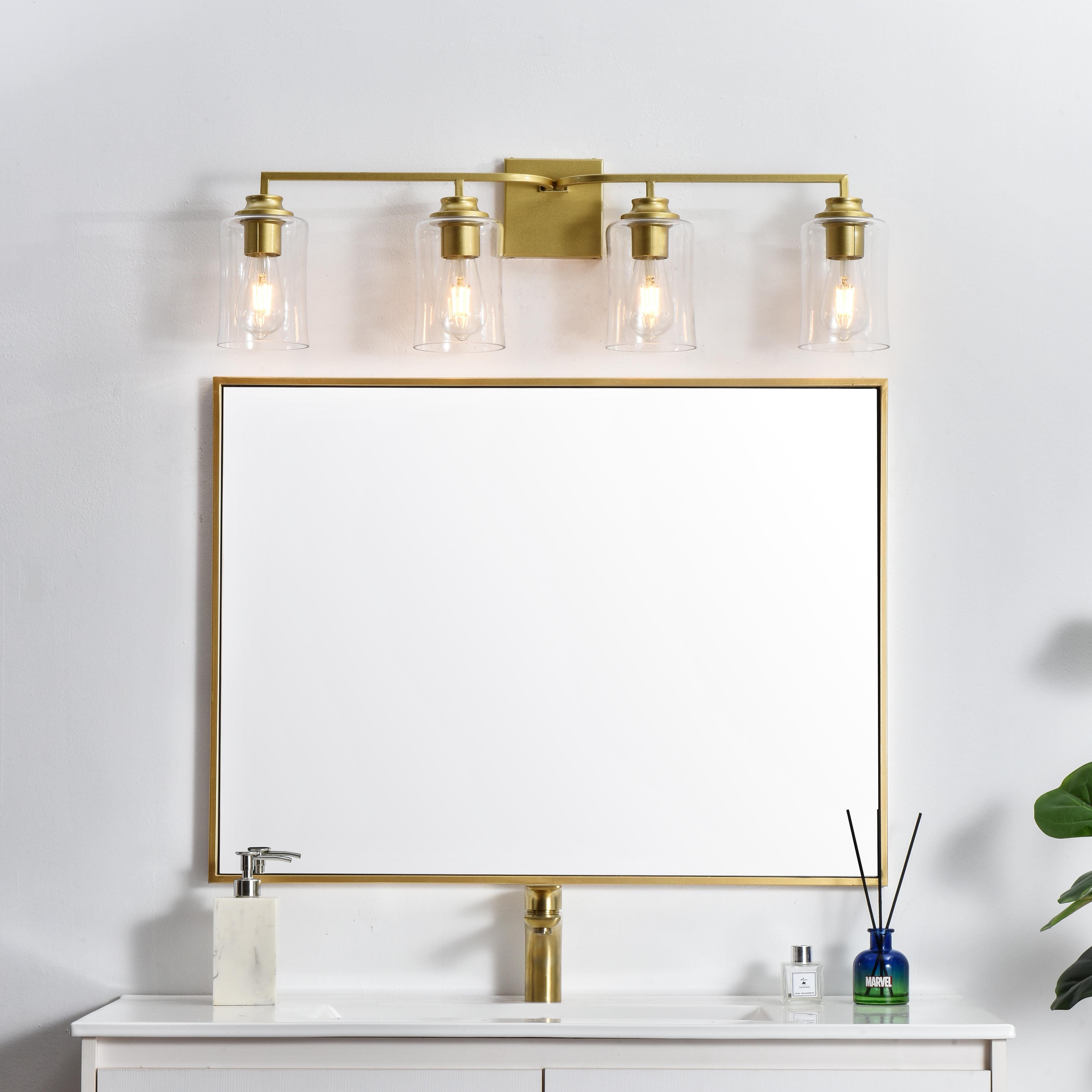 Specification Sheet
Dimensions
Length: 6"
Width: 32"
Height: 9"
Extension: 6"
Wire Length: 8"
Depth: 6"
Specifications
Assembly Required: Yes
Bulb Included: No
#N/A
Dimmable: Yes
Distressed Finish: No
Dry/Wet/Damp: Damp
ETL: yes
Finish (Color): Brass and Clear
Fixture Material: Iron and Glass
Hardware Finish: Brass
Harware Material: Iron
Max/Nominal Watt: 160W
Number of Lights: 4
Product Type: Vanity Lights
Product Warranty: 1 year limited
Socket Type: E26
Voltage: 110V
Wattage/Bulb: 40W
Weight: 6
Wire Included: Yes
Shipment type: Small Parcel
US Shipping Cost: $13.00 - alternate view