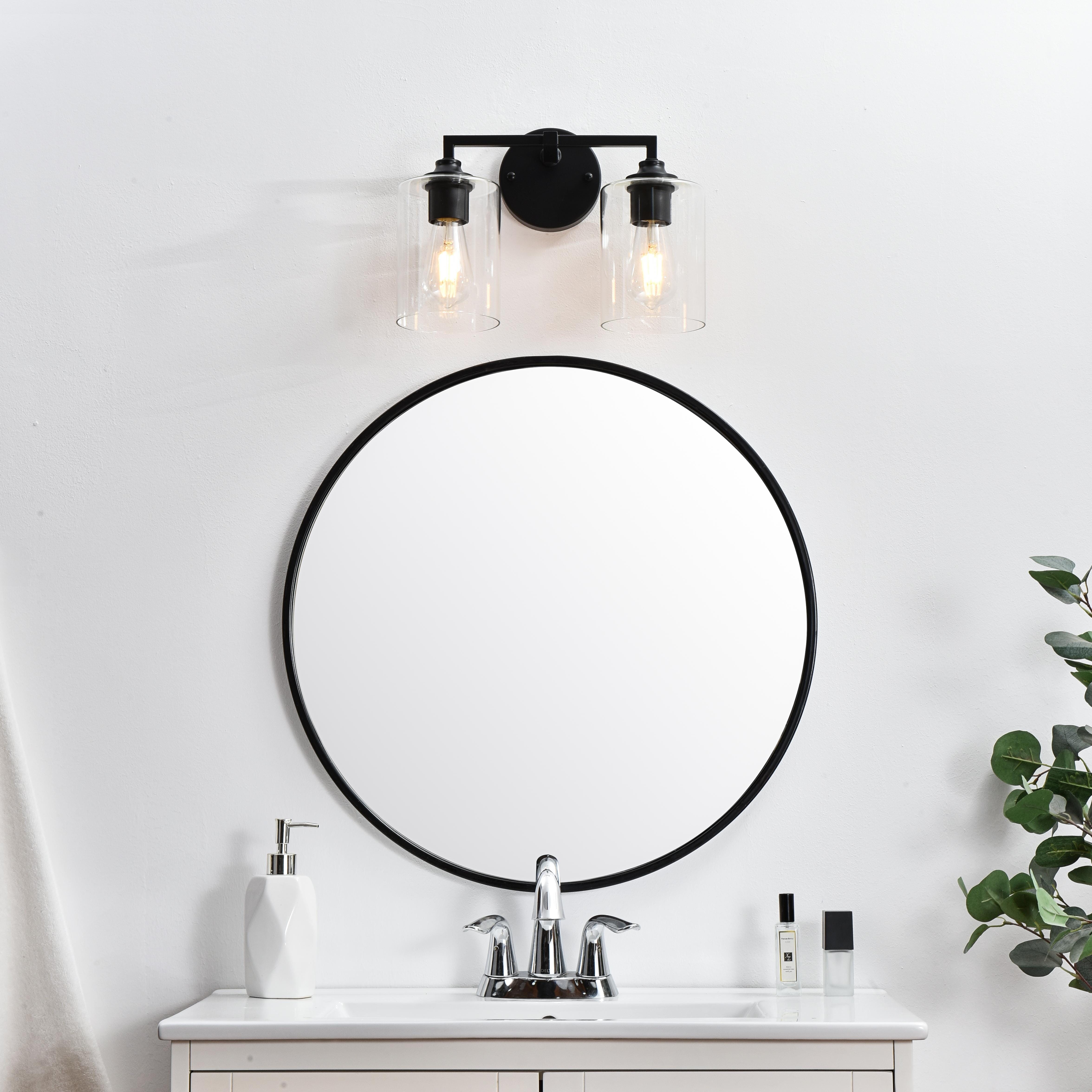 Specification Sheet
Dimensions
Length: 6.7"
Width: 14"
Height: 10"
Extension: 7"
Wire Length: 8"
Depth: 7"
Specifications
Assembly Required: Yes
Bulb Included: No
#N/A
Dimmable: Yes
Distressed Finish: No
Dry/Wet/Damp: Damp
ETL: yes
Finish (Color): Black and Clear
Fixture Material: Iron and Glass
Hardware Finish: Black
Harware Material: Iron
Max/Nominal Watt: 80W
Number of Lights: 2
Product Type: Vanity Lights
Product Warranty: 1 year limited
Socket Type: E26
Voltage: 110V
Wattage/Bulb: 40W
Weight: 3
Wire Included: Yes
Shipment type: Small Parcel
US Shipping Cost: $13.00 - alternate view