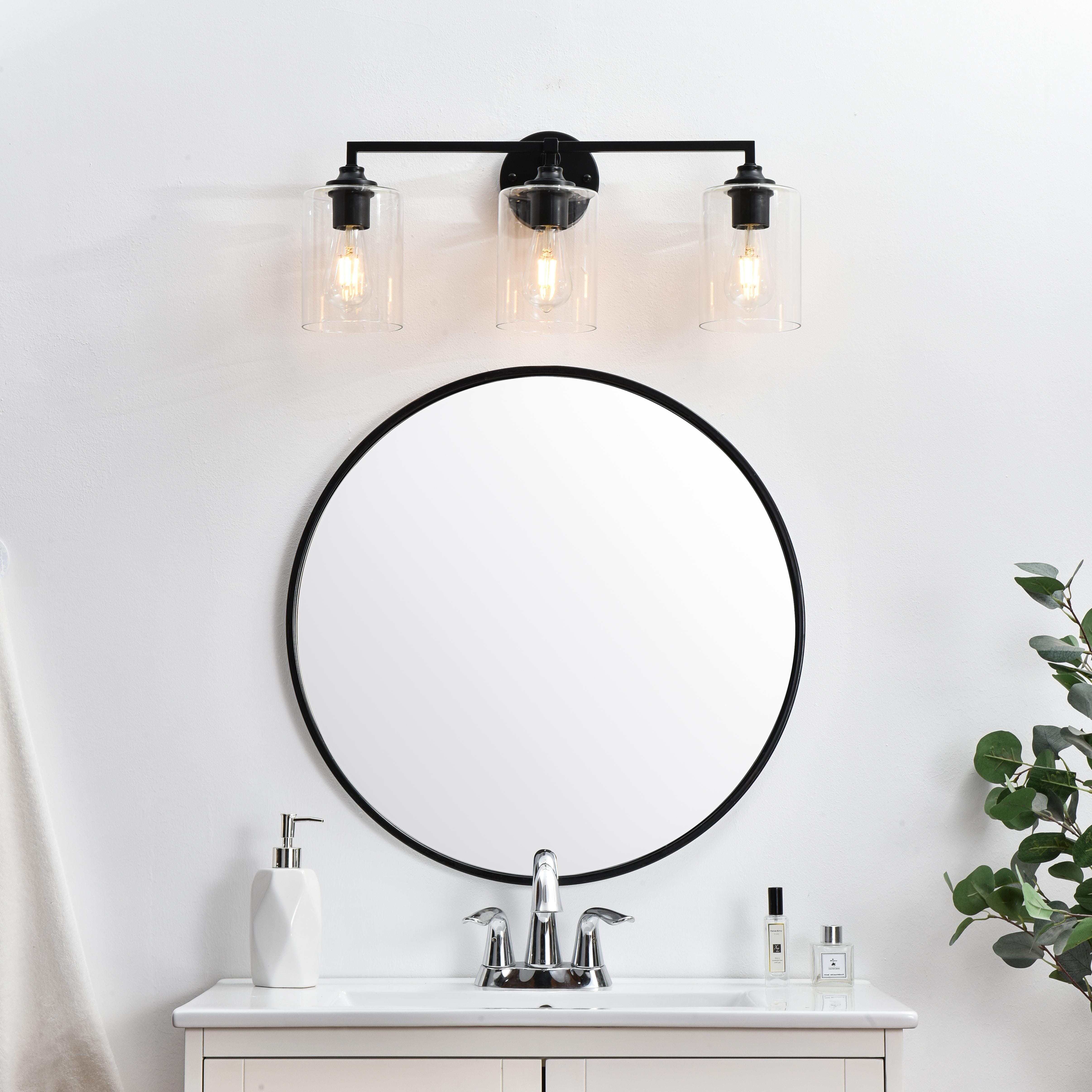 Specification Sheet
Dimensions
Length: 6.7"
Width: 23"
Height: 10"
Extension: 7"
Wire Length: 8"
Depth: 7"
Specifications
Assembly Required: Yes
Bulb Included: No
#N/A
Dimmable: Yes
Distressed Finish: No
Dry/Wet/Damp: Damp
ETL: yes
Finish (Color): Black and Clear
Fixture Material: Iron and Glass
Hardware Finish: Black
Harware Material: Iron
Max/Nominal Watt: 120W
Number of Lights: 3
Product Type: Vanity Lights
Product Warranty: 1 year limited
Socket Type: E26
Voltage: 110V
Wattage/Bulb: 40W
Weight: 4
Wire Included: Yes
Shipment type: Small Parcel
US Shipping Cost: $13.00 - alternate view