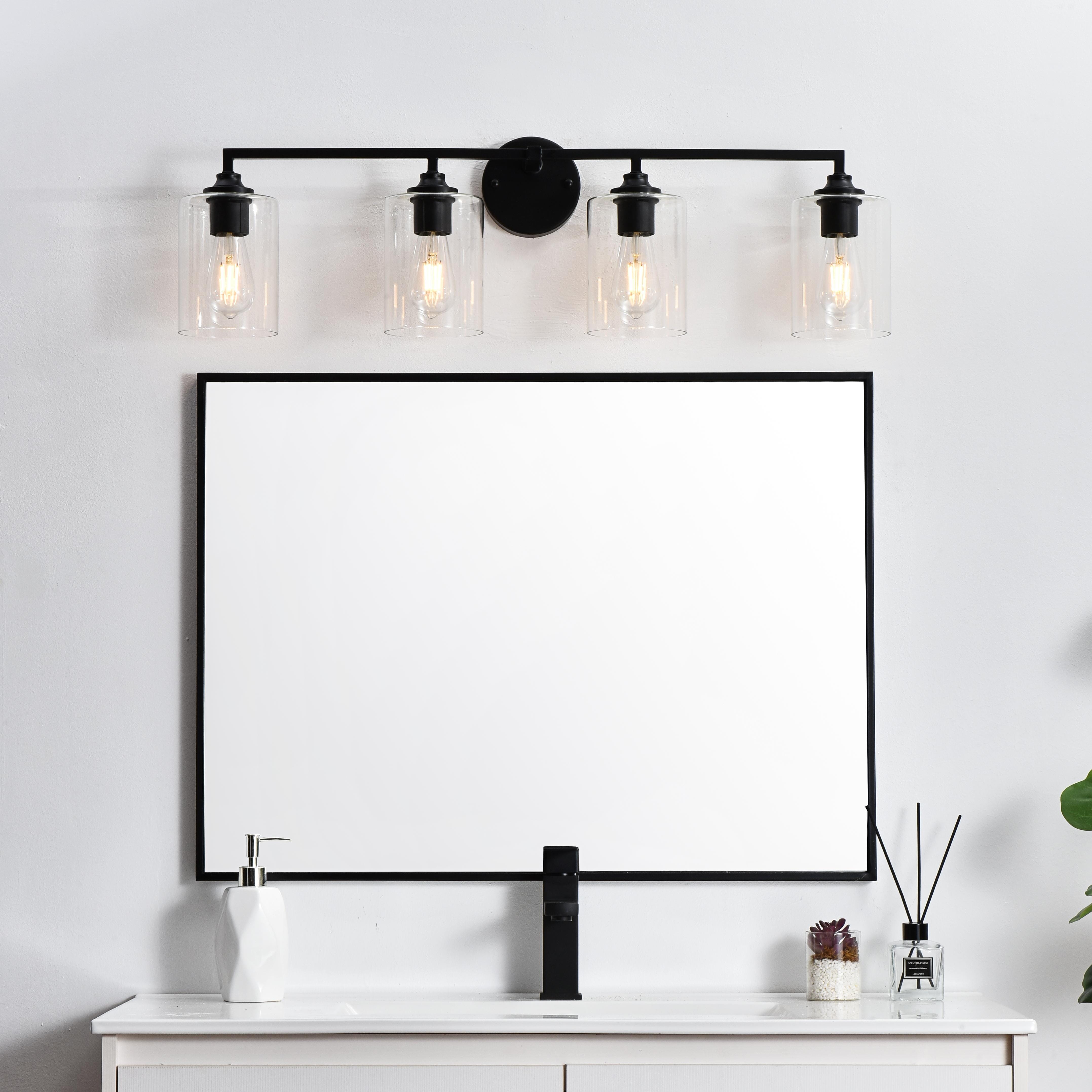 Specification Sheet
Dimensions
Length: 6.7"
Width: 33"
Height: 10"
Extension: 7"
Wire Length: 8"
Depth: 7"
Specifications
Assembly Required: Yes
Bulb Included: No
#N/A
Dimmable: Yes
Distressed Finish: No
Dry/Wet/Damp: Damp
ETL: yes
Finish (Color): Black and Clear
Fixture Material: Iron and Glass
Hardware Finish: Black
Harware Material: Iron
Max/Nominal Watt: 160W
Number of Lights: 4
Product Type: Vanity Lights
Product Warranty: 1 year limited
Socket Type: E26
Voltage: 110V
Wattage/Bulb: 40W
Weight: 5
Wire Included: Yes
Shipment type: Small Parcel
US Shipping Cost: $14.00 - alternate view