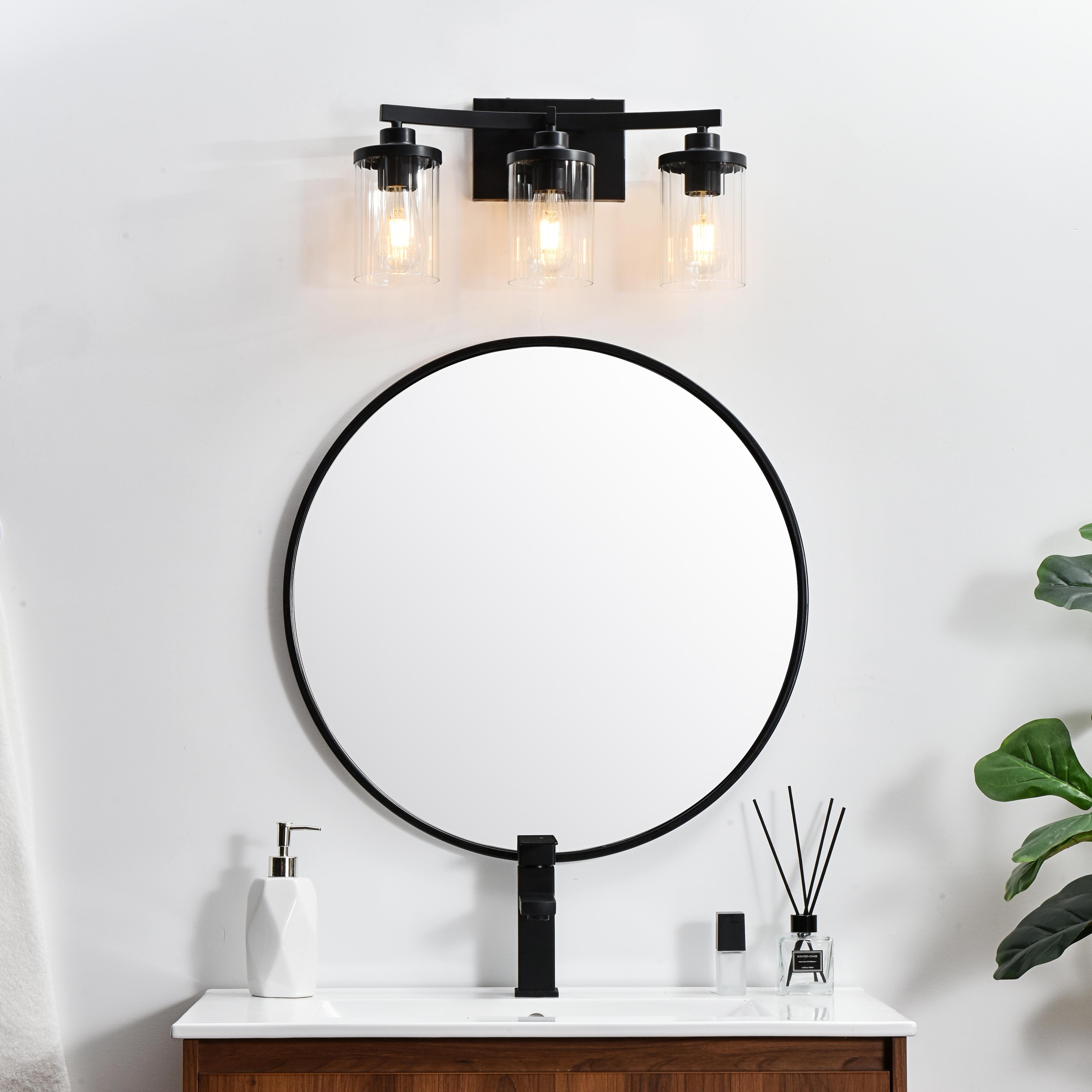 Specification Sheet
Dimensions
Length: 5.6"
Width: 18"
Height: 10"
Extension: 6"
Wire Length: 8"
Depth: 6"
Specifications
Assembly Required: Yes
Bulb Included: No
#N/A
Dimmable: Yes
Distressed Finish: No
Dry/Wet/Damp: Damp
ETL: yes
Finish (Color): Black and Clear
Fixture Material: Iron and Glass
Hardware Finish: Black
Harware Material: Iron
Max/Nominal Watt: 120W
Number of Lights: 3
Product Type: Vanity Lights
Product Warranty: 1 year limited
Socket Type: E26
Voltage: 110V
Wattage/Bulb: 40W
Weight: 4
Wire Included: Yes
Shipment type: Small Parcel
US Shipping Cost: $13.00 - alternate view