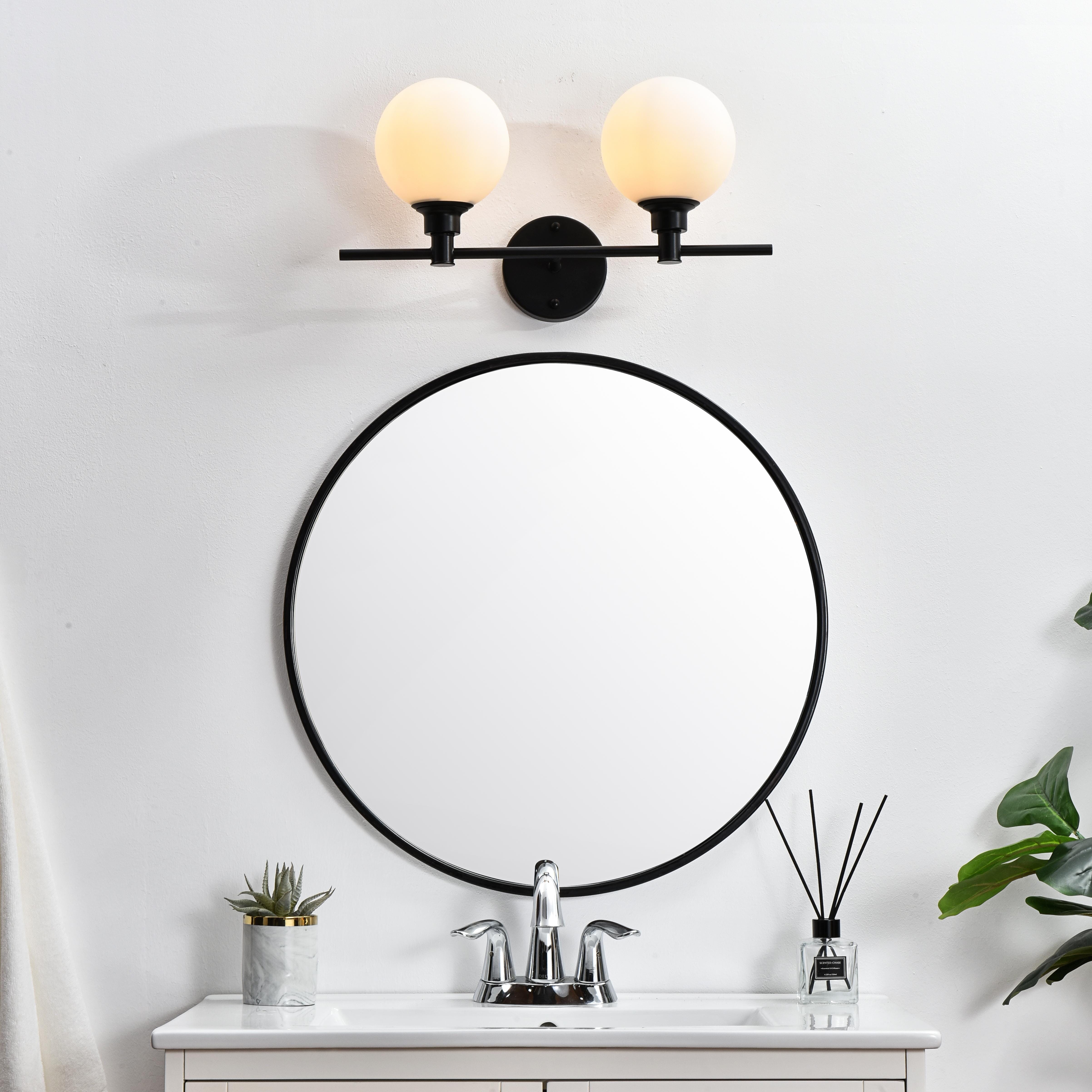 Specification Sheet
Dimensions
Length: 7.7"
Width: 19"
Height: 10"
Extension: 8"
Wire Length: 8"
Depth: 8"
Specifications
Assembly Required: Yes
Bulb Included: No
#N/A
Dimmable: Yes
Distressed Finish: No
Dry/Wet/Damp: Damp
ETL: yes
Finish (Color): Black and Frosted White
Fixture Material: Iron and Glass
Hardware Finish: Black
Harware Material: Iron
Max/Nominal Watt: 80W
Number of Lights: 2
Product Type: Vanity Lights
Product Warranty: 1 year limited
Socket Type: E12
Voltage: 110V
Wattage/Bulb: 40W
Weight: 3
Wire Included: Yes
Shipment type: Small Parcel
US Shipping Cost: $13.00 - alternate view