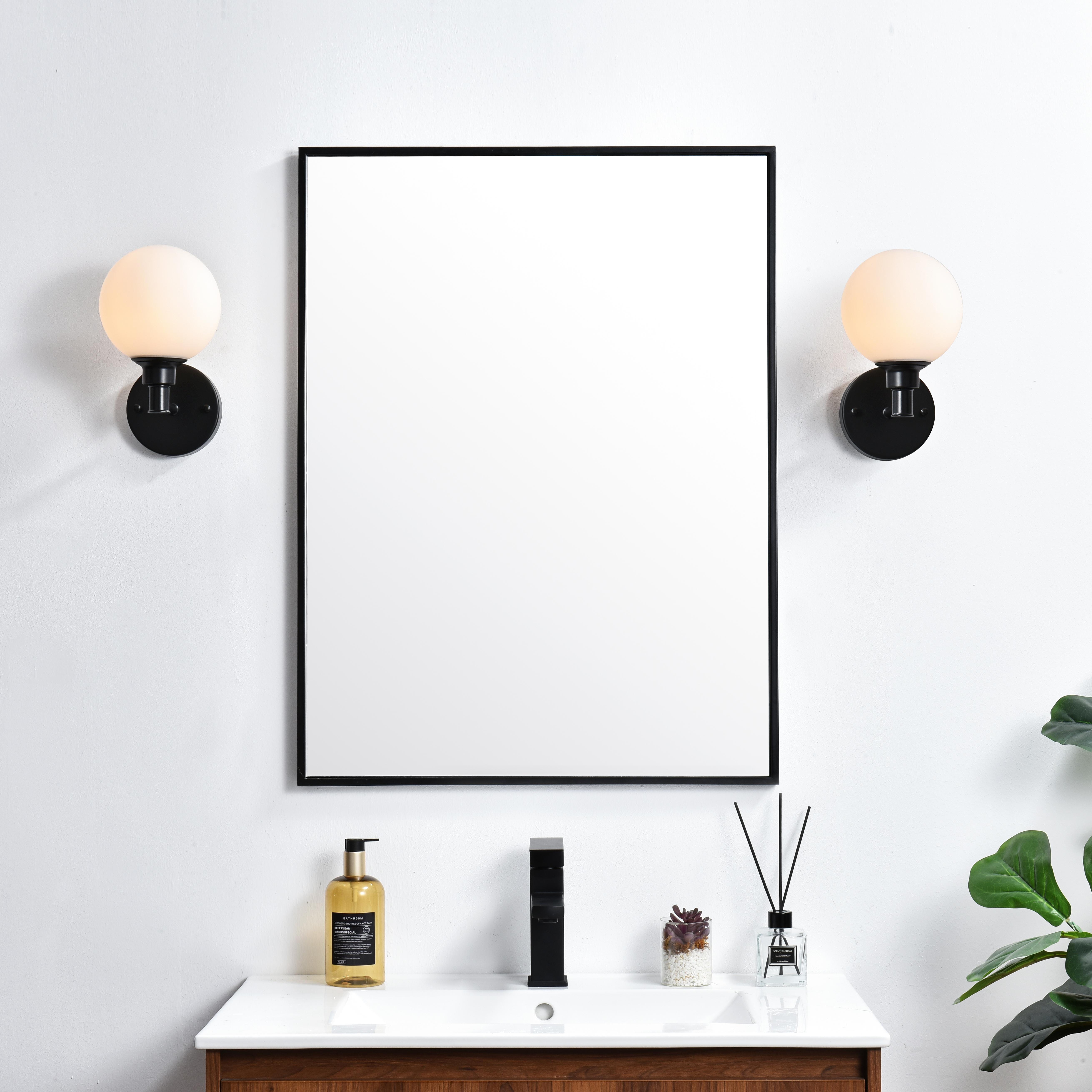 Specification Sheet
Dimensions
Length: 7.7"
Width: 6"
Height: 10"
Extension: 8"
Wire Length: 8"
Depth: 8"
Specifications
Assembly Required: Yes
Bulb Included: No
#N/A
Dimmable: Yes
Distressed Finish: No
Dry/Wet/Damp: Damp
ETL: yes
Finish (Color): Black and Frosted White
Fixture Material: Iron and Glass
Hardware Finish: Black
Harware Material: Iron
Max/Nominal Watt: 40W
Number of Lights: 1
Product Type: Vanity Lights
Product Warranty: 1 year limited
Socket Type: E12
Voltage: 110V
Wattage/Bulb: 40W
Weight: 2
Wire Included: Yes
Shipment type: Small Parcel
US Shipping Cost: $13.00 - alternate view