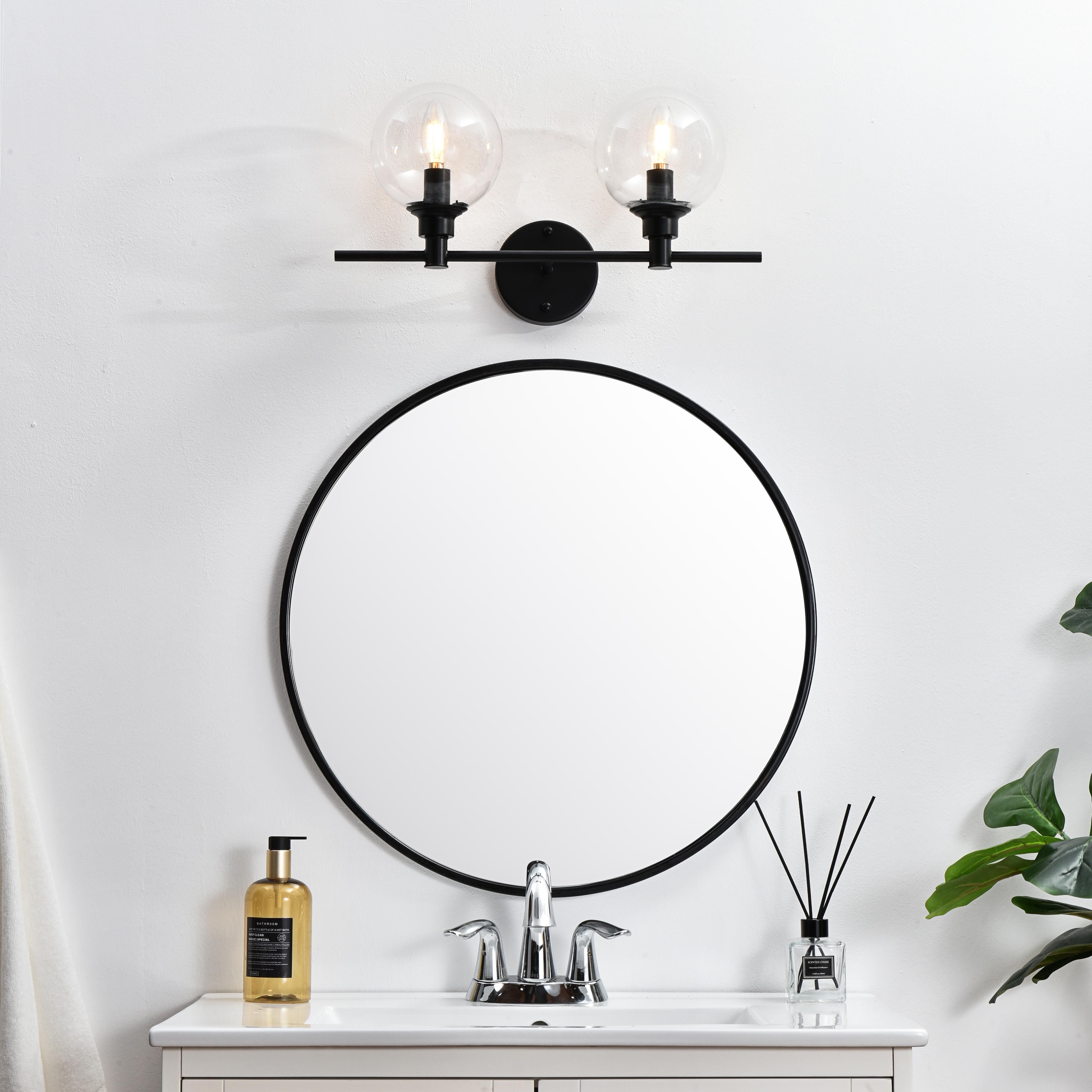 Specification Sheet
Dimensions
Length: 7.7"
Width: 19"
Height: 10"
Extension: 8"
Wire Length: 8"
Depth: 8"
Specifications
Assembly Required: Yes
Bulb Included: No
#N/A
Dimmable: Yes
Distressed Finish: No
Dry/Wet/Damp: Damp
ETL: yes
Finish (Color): Black and Clear
Fixture Material: Iron and Glass
Hardware Finish: Black
Harware Material: Iron
Max/Nominal Watt: 80W
Number of Lights: 2
Product Type: Vanity Lights
Product Warranty: 1 year limited
Socket Type: E12
Voltage: 110V
Wattage/Bulb: 40W
Weight: 3
Wire Included: Yes
Shipment type: Small Parcel
US Shipping Cost: $13.00 - alternate view