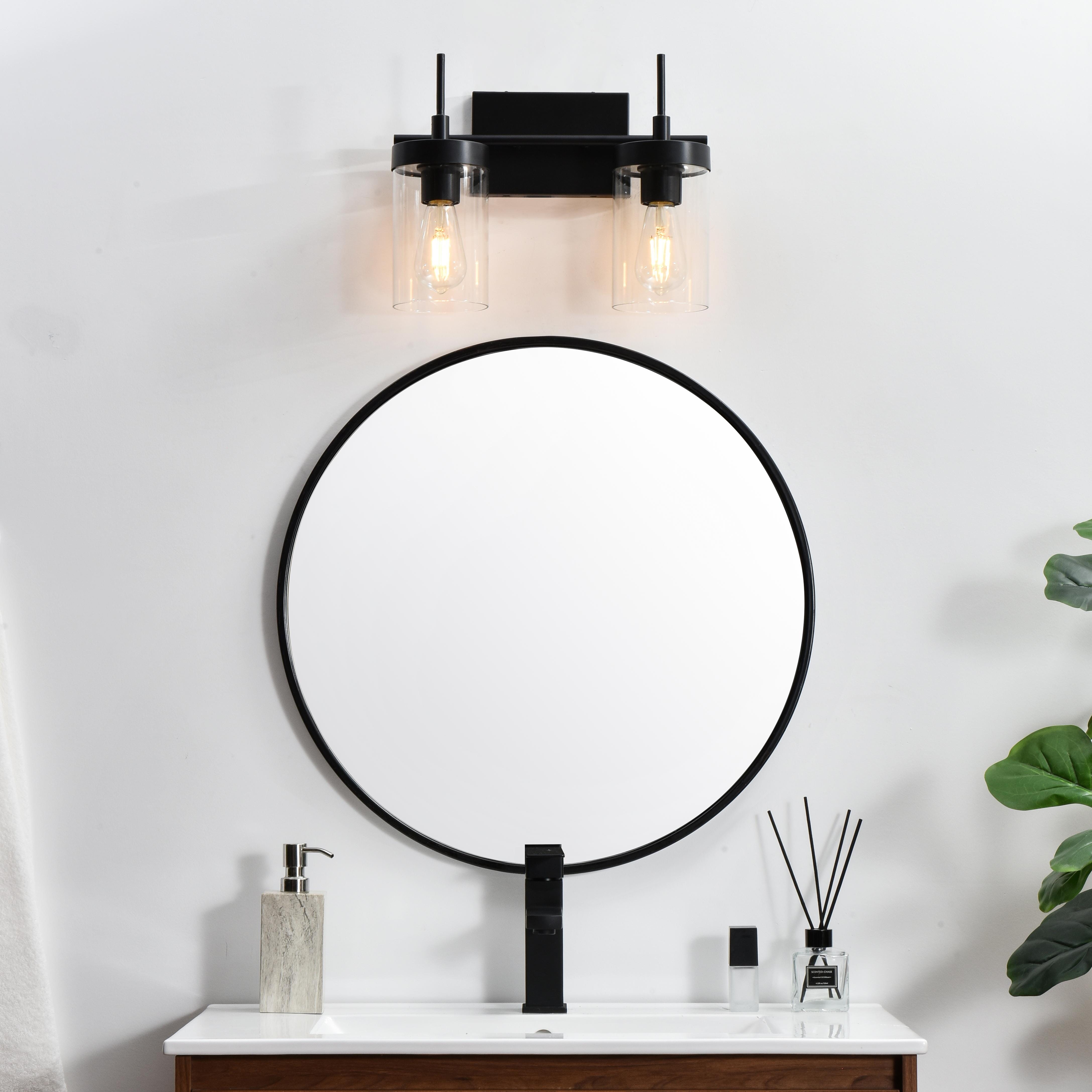 Specification Sheet
Dimensions
Length: 5.8"
Width: 14"
Height: 11"
Extension: 6"
Wire Length: 8"
Depth: 6"
Specifications
Assembly Required: Yes
Bulb Included: No
#N/A
Dimmable: Yes
Distressed Finish: No
Dry/Wet/Damp: Damp
ETL: yes
Finish (Color): Black and Clear
Fixture Material: Iron and Glass
Hardware Finish: Black
Harware Material: Iron
Max/Nominal Watt: 80W
Number of Lights: 2
Product Type: Vanity Lights
Product Warranty: 1 year limited
Socket Type: E26
Voltage: 110V
Wattage/Bulb: 40W
Weight: 4
Wire Included: Yes
Shipment type: Small Parcel
US Shipping Cost: $13.00 - alternate view