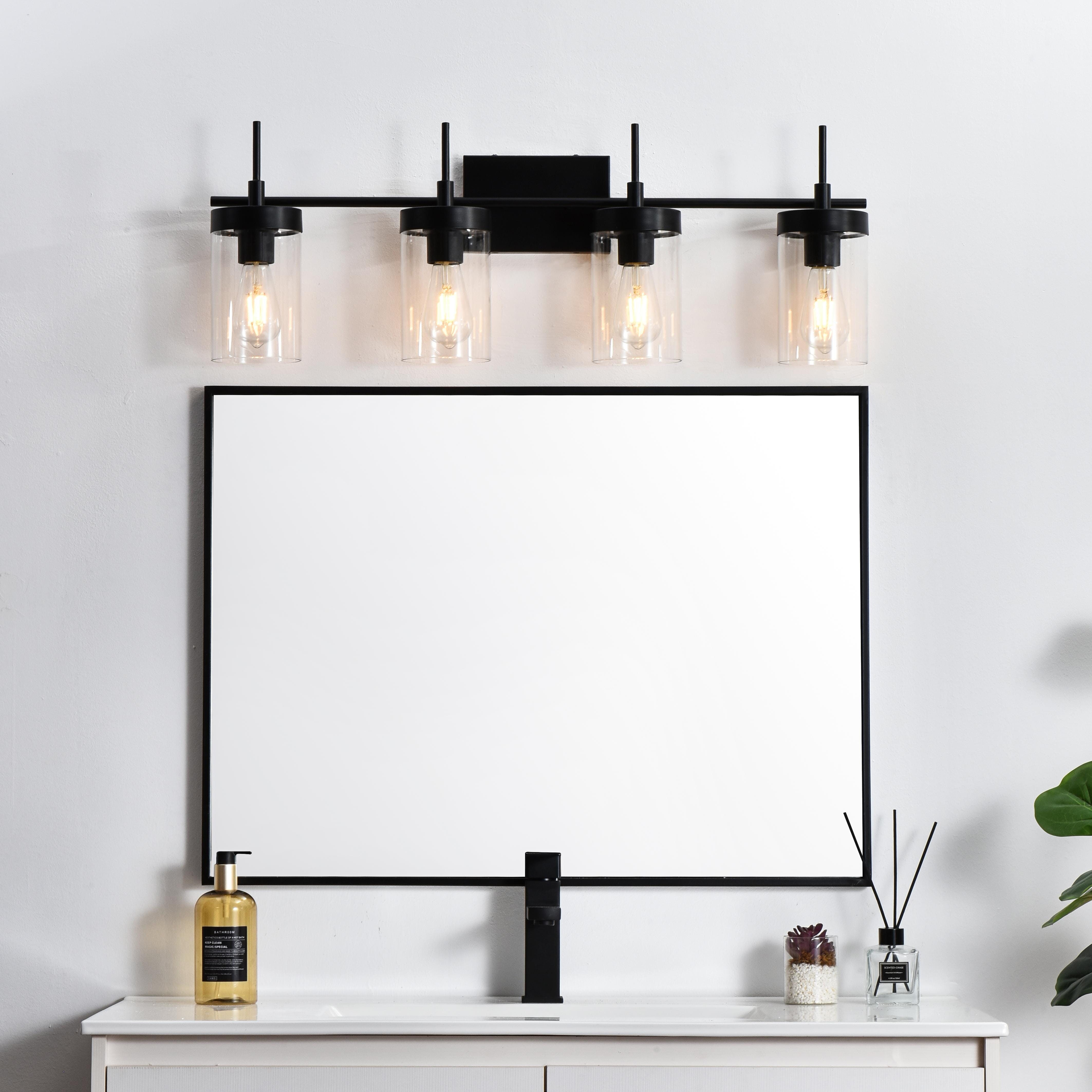 Specification Sheet
Dimensions
Length: 5.8"
Width: 32"
Height: 11"
Extension: 6"
Wire Length: 8"
Depth: 6"
Specifications
Assembly Required: Yes
Bulb Included: No
#N/A
Dimmable: Yes
Distressed Finish: No
Dry/Wet/Damp: Damp
ETL: yes
Finish (Color): Black and Clear
Fixture Material: Iron and Glass
Hardware Finish: Black
Harware Material: Iron
Max/Nominal Watt: 160W
Number of Lights: 4
Product Type: Vanity Lights
Product Warranty: 1 year limited
Socket Type: E26
Voltage: 110V
Wattage/Bulb: 40W
Weight: 7
Wire Included: Yes
Shipment type: Small Parcel
US Shipping Cost: $15.00 - alternate view