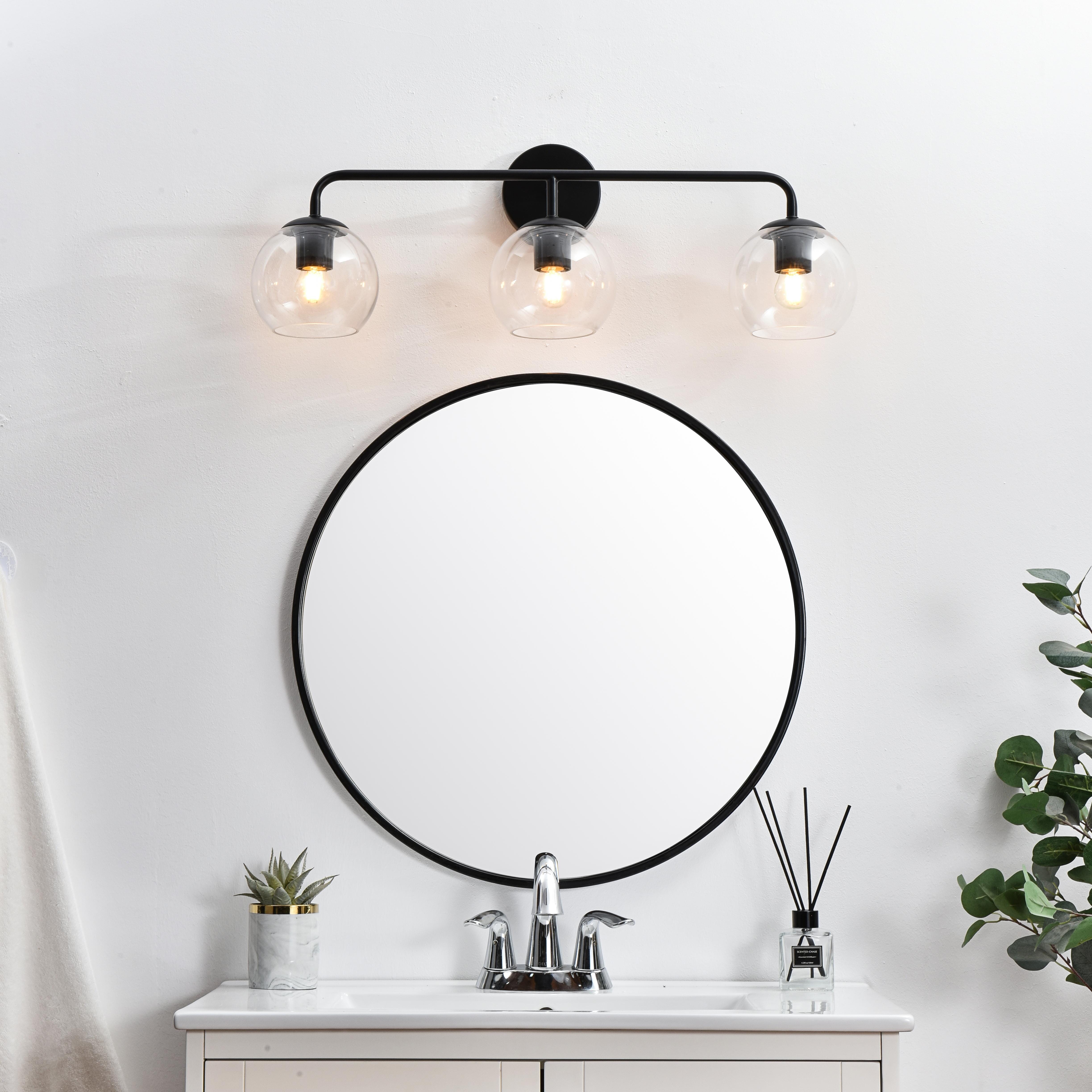 Specification Sheet
Dimensions
Length: 7.7"
Width: 28"
Height: 10"
Extension: 8"
Wire Length: 8"
Depth: 8"
Specifications
Assembly Required: Yes
Bulb Included: No
#N/A
Dimmable: Yes
Distressed Finish: No
Dry/Wet/Damp: Damp
ETL: yes
Finish (Color): Black and Clear
Fixture Material: Iron and Glass
Hardware Finish: Black
Harware Material: Iron
Max/Nominal Watt: 120W
Number of Lights: 3
Product Type: Vanity Lights
Product Warranty: 1 year limited
Socket Type: E26
Voltage: 110V
Wattage/Bulb: 40W
Weight: 3
Wire Included: Yes
Shipment type: Small Parcel
US Shipping Cost: $15.00 - alternate view