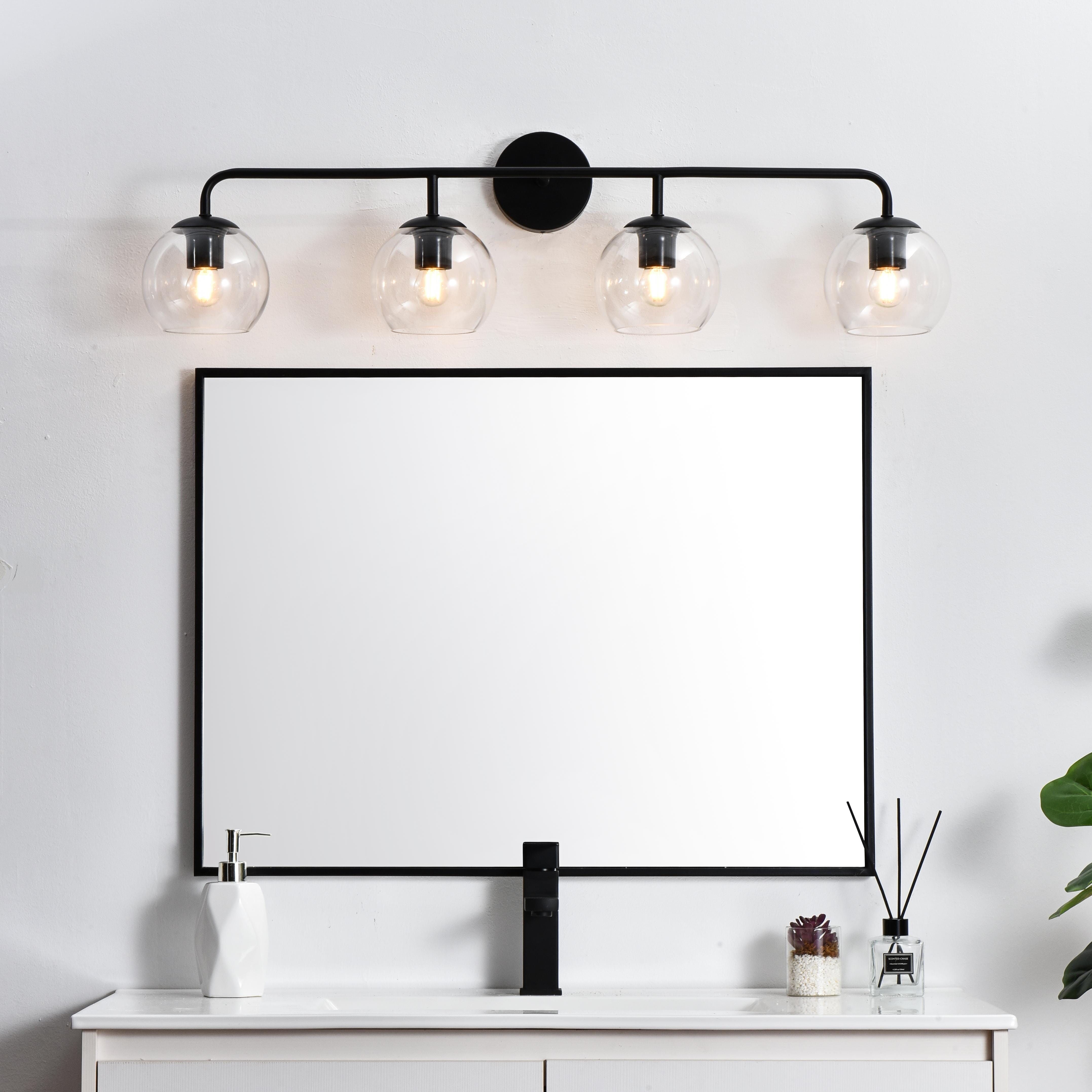 Specification Sheet
Dimensions
Length: 7.7"
Width: 37"
Height: 10"
Extension: 8"
Wire Length: 8"
Depth: 8"
Specifications
Assembly Required: Yes
Bulb Included: No
#N/A
Dimmable: Yes
Distressed Finish: No
Dry/Wet/Damp: Damp
ETL: yes
Finish (Color): Black and Clear
Fixture Material: Iron and Glass
Hardware Finish: Black
Harware Material: Iron
Max/Nominal Watt: 160W
Number of Lights: 4
Product Type: Vanity Lights
Product Warranty: 1 year limited
Socket Type: E26
Voltage: 110V
Wattage/Bulb: 40W
Weight: 4
Wire Included: Yes
Shipment type: Small Parcel
US Shipping Cost: $17.00 - alternate view