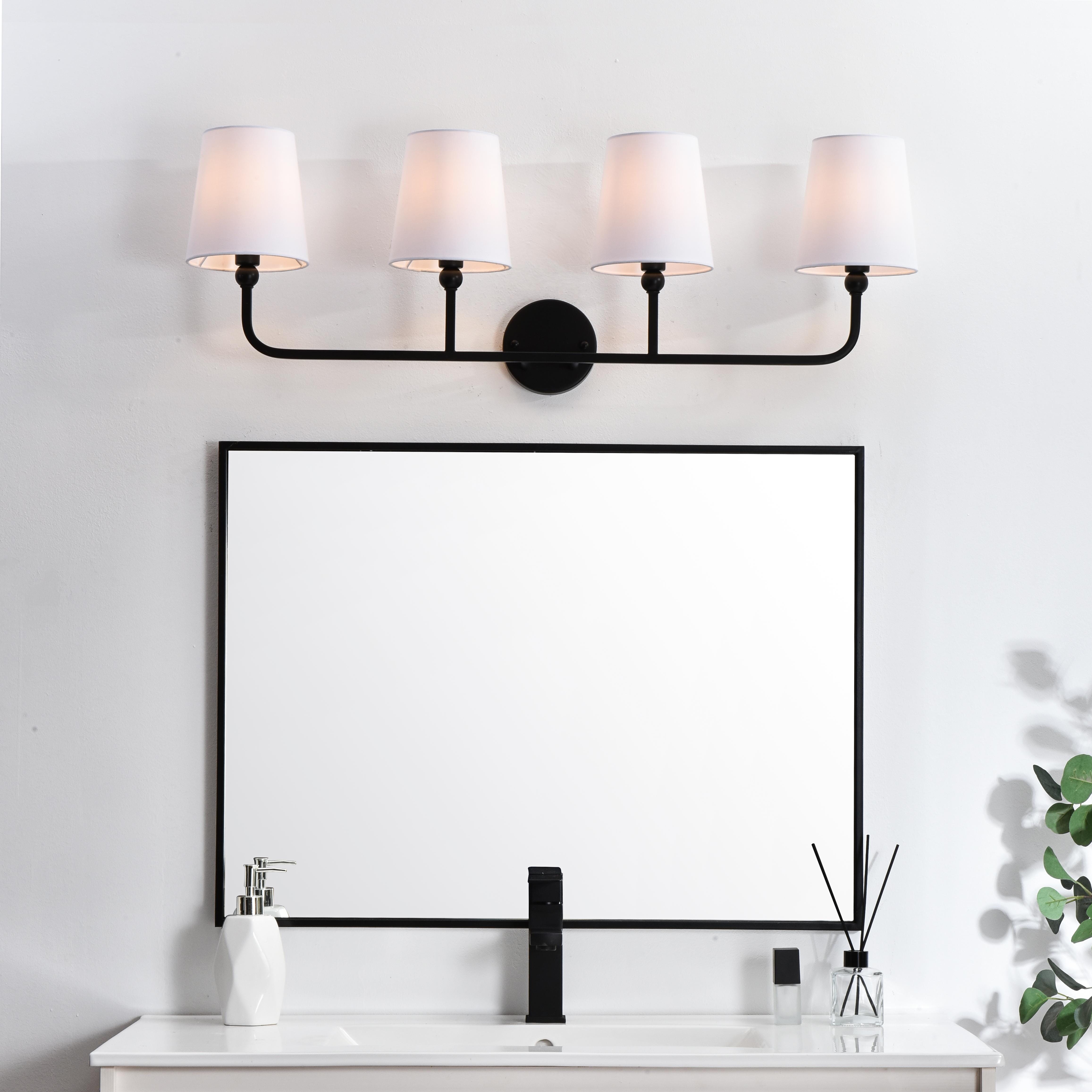 Specification Sheet
Dimensions
Length: 7.5"
Width: 36"
Height: 12"
Extension: 7.5"
Wire Length: 8"
Depth: 8"
Specifications
Assembly Required: Yes
Bulb Included: No
#N/A
Dimmable: Yes
Distressed Finish: No
Dry/Wet/Damp: Damp
ETL: yes
Finish (Color): Black and Clear
Fixture Material: Metal and Fabric shade
Hardware Finish: Black
Harware Material: Iron
Max/Nominal Watt: 160W
Number of Lights: 4
Product Type: Vanity Lights
Product Warranty: 1 year limited
Socket Type: E12
Voltage: 110V
Wattage/Bulb: 40W
Weight: 3
Wire Included: Yes
Shipment type: Small Parcel
US Shipping Cost: $14.00 - alternate view