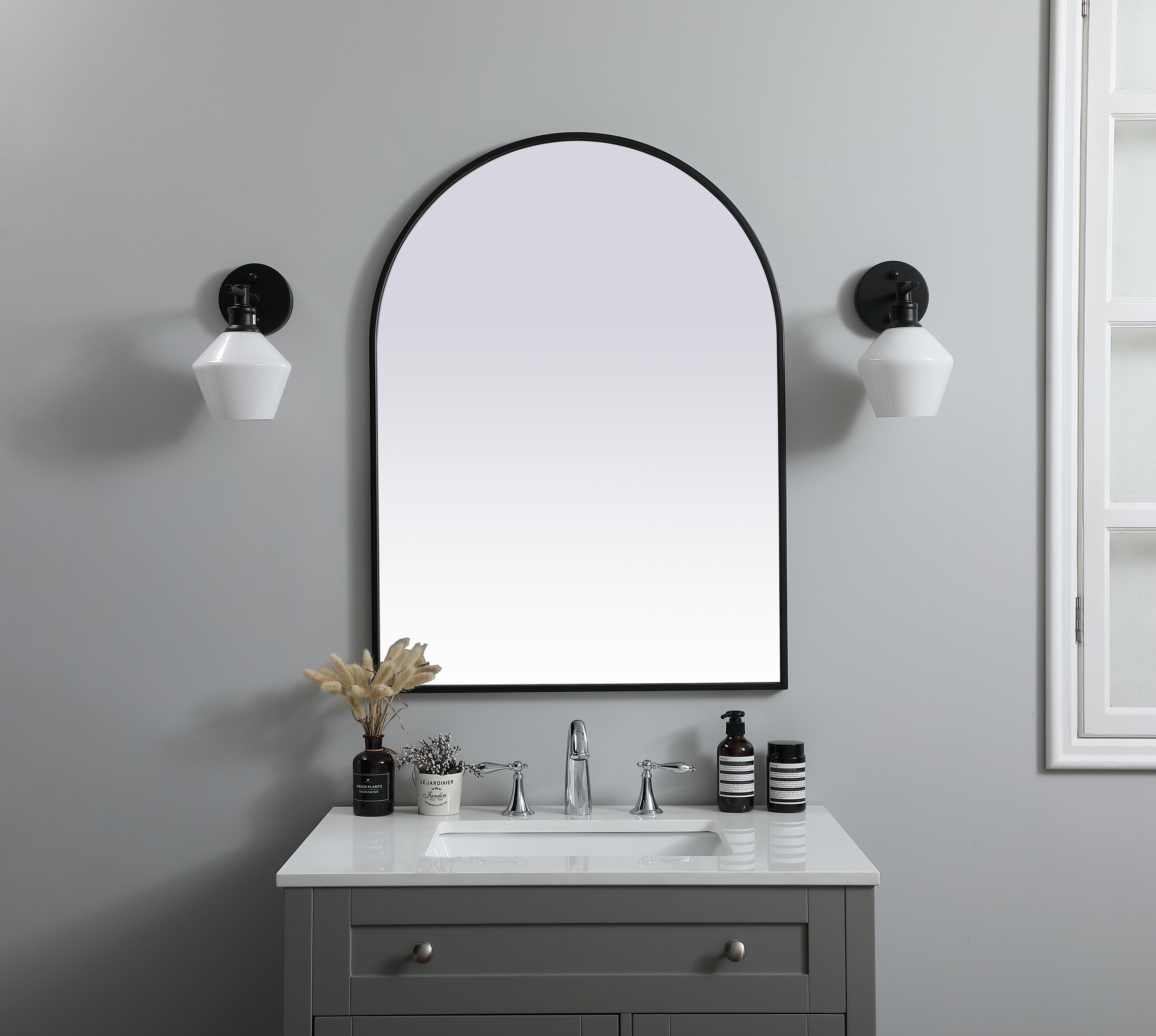 Specification Sheet
Dimensions
Length: 36"
Width: 27"
Height: 36"
Depth: 1"
Specifications
Assembly Required: NO
Distressed Finish: No
Finish (Color): Black
Fixture Material: Iron and MDF
Frameless: NO
Mirror Frame Shape: Arch
Mirror Hanging Orientation: Vertical
Mirror Mounting: Metal Inset hanger
Mirror Type: Flat
Product Shape: Arch
Product Type: Decorative Mirrors
Product Warranty: 1 year limited
Weight: 16.84
Wire Included: No
Shipment type: small parcel
US Shipping Cost: $25.00 - alternate view