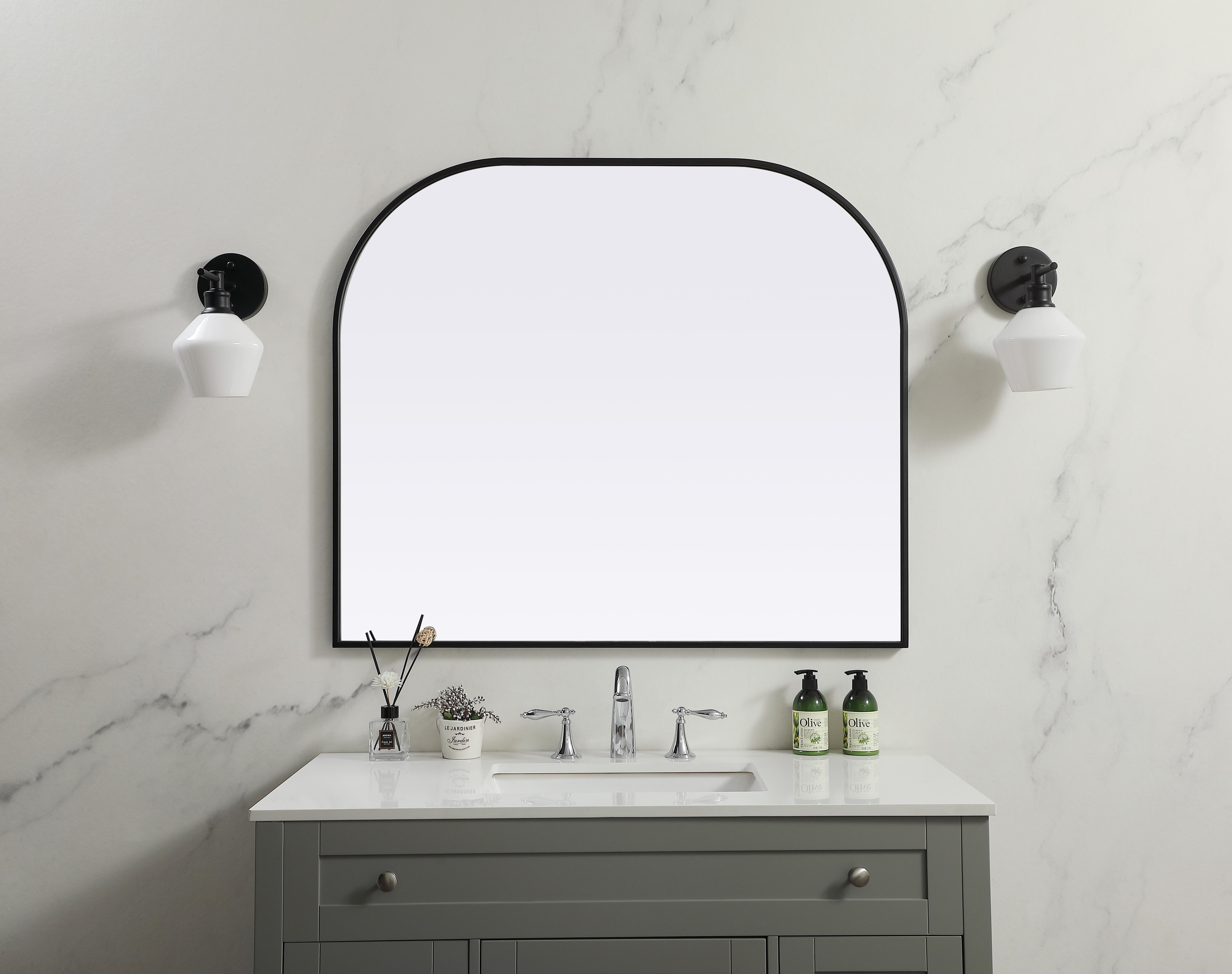 Specification Sheet
Dimensions
Length: 34"
Width: 40"
Height: 34"
Depth: 1"
Specifications
Assembly Required: NO
Distressed Finish: No
Finish (Color): Black
Fixture Material: Iron and MDF
Frameless: NO
Mirror Frame Shape: Arch
Mirror Hanging Orientation: Vertical
Mirror Mounting: Metal Inset hanger
Mirror Type: Flat
Product Shape: Arch
Product Type: Decorative Mirrors
Product Warranty: 1 year limited
Weight: 21.63
Wire Included: No
Shipment type: small parcel
US Shipping Cost: $29.00 - alternate view