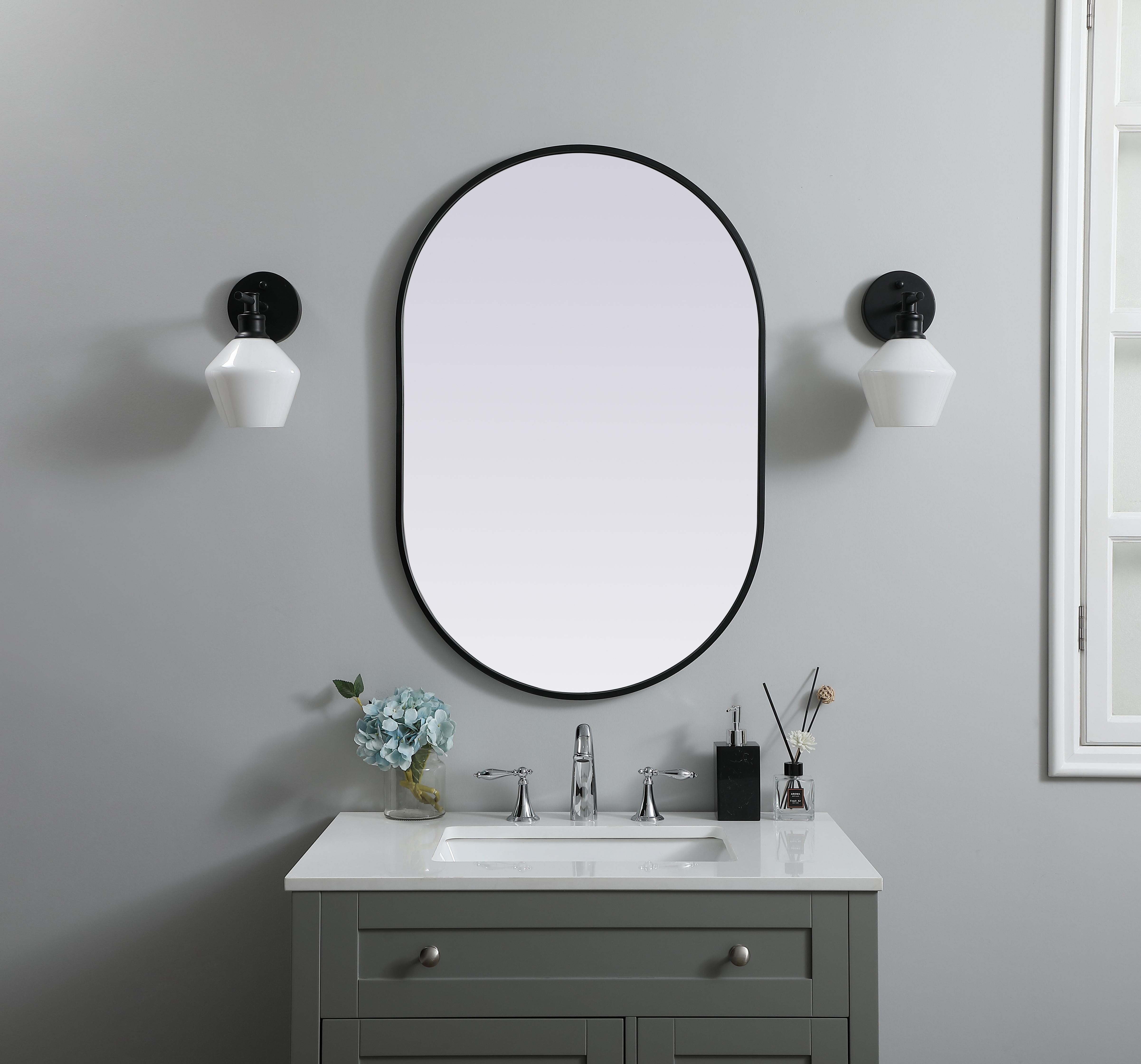 Specification Sheet
Dimensions
Length: 36"
Width: 24"
Height: 36"
Depth: 1"
Specifications
Assembly Required: NO
Distressed Finish: No
Finish (Color): Black
Fixture Material: Iron and MDF
Frameless: NO
Mirror Frame Shape: Oval
Mirror Hanging Orientation: Vertical and Horizontal
Mirror Mounting: Metal Inset hanger
Mirror Type: Flat
Product Shape: Oval
Product Type: Decorative Mirrors
Product Warranty: 1 year limited
Weight: 13.93
Wire Included: No
Shipment type: small parcel
US Shipping Cost: $16.00 - alternate view
