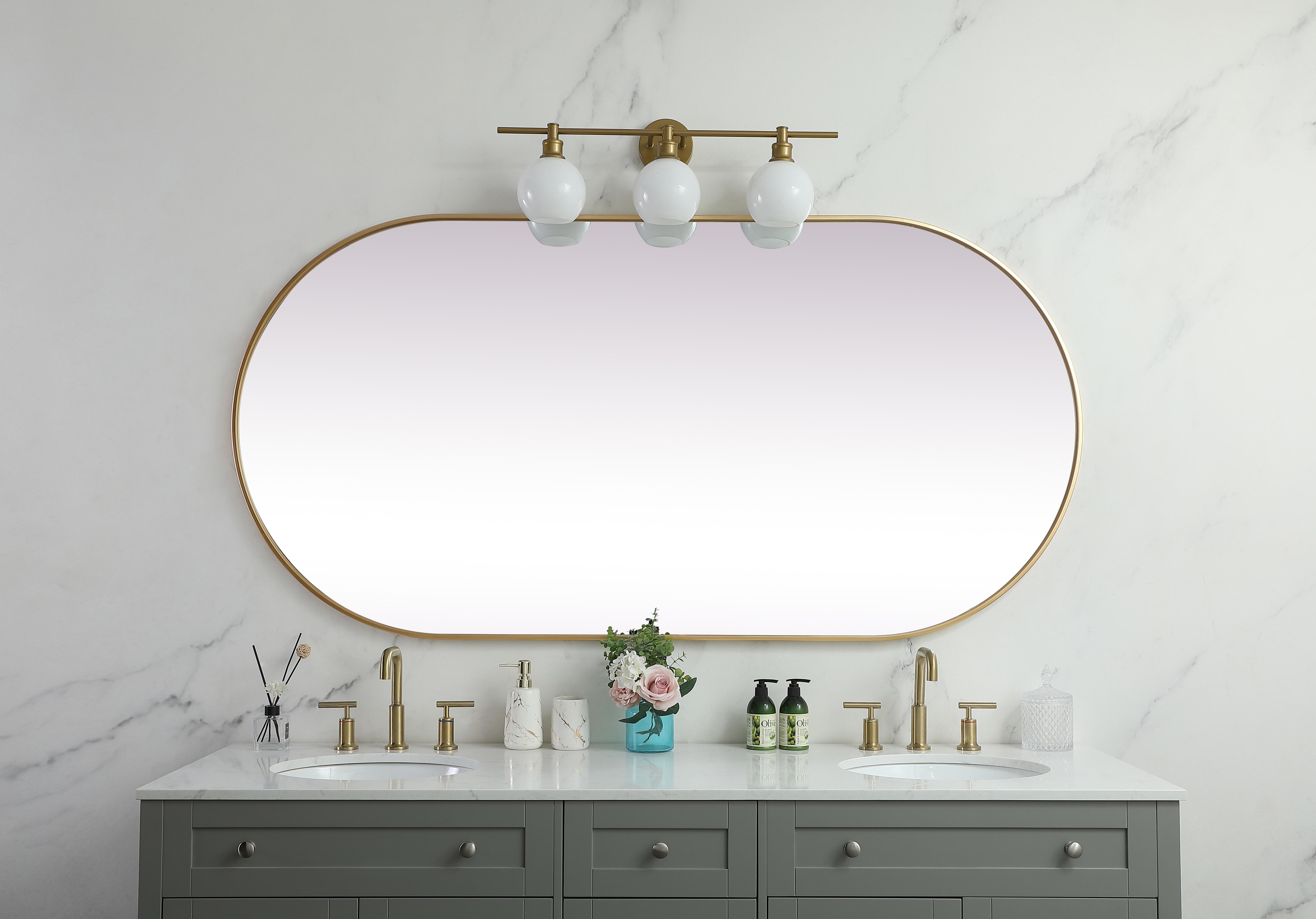 Asha Pill-Shaped Wall Mirror in Brass - Image 4