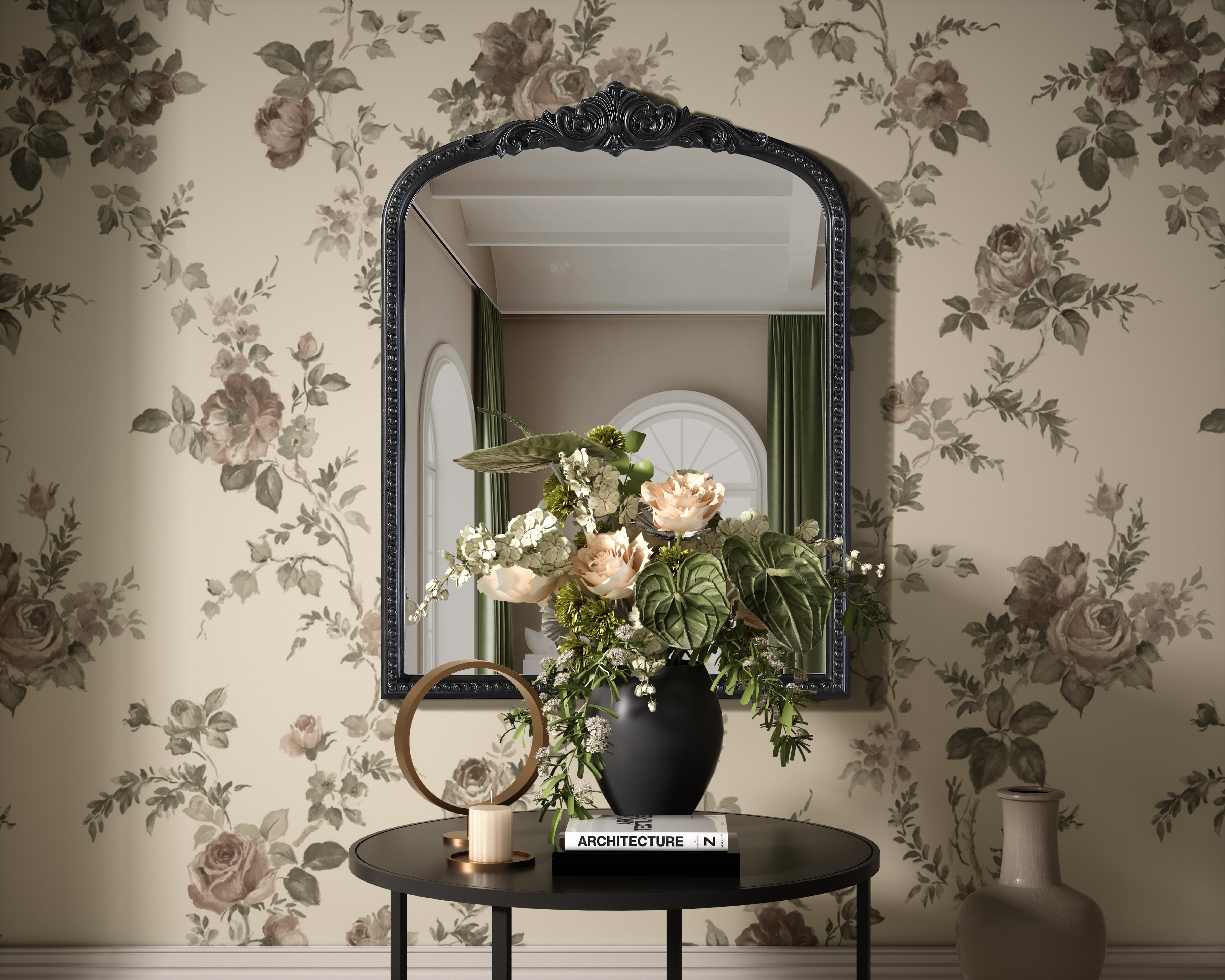 Bring classic charm and vintage character to your home with this arched wall mirror in a distressed vintage bronze finish. The hand-painted frame showcases ornate scroll and floral detailing, creating a refined, old-world aesthetic. Crafted from resin with an MDF backing board, this mirror is lightweight yet durable. Designed for vertical hanging only, it includes a metal inset hanger for easy installation (hardware not included). Whether placed above a fireplace mantel, in an entryway, or as an accent piece in a living room, this mirror enhances the space with its architectural beauty. Available in multiple sizes and an alternative antique brass finish, it is a versatile addition to classic, vintage, or French-inspired interiors. Collection: Naomi Rooms: entry way, living room, dining room, bedroom, office Finish: Vintage Bronze Width: 27.00" Height: 36.00" Weight: 19.00 lb Material: Resin Country of Origin: Vietnam Manufacturer Warranty: 1 year limited - alternate view