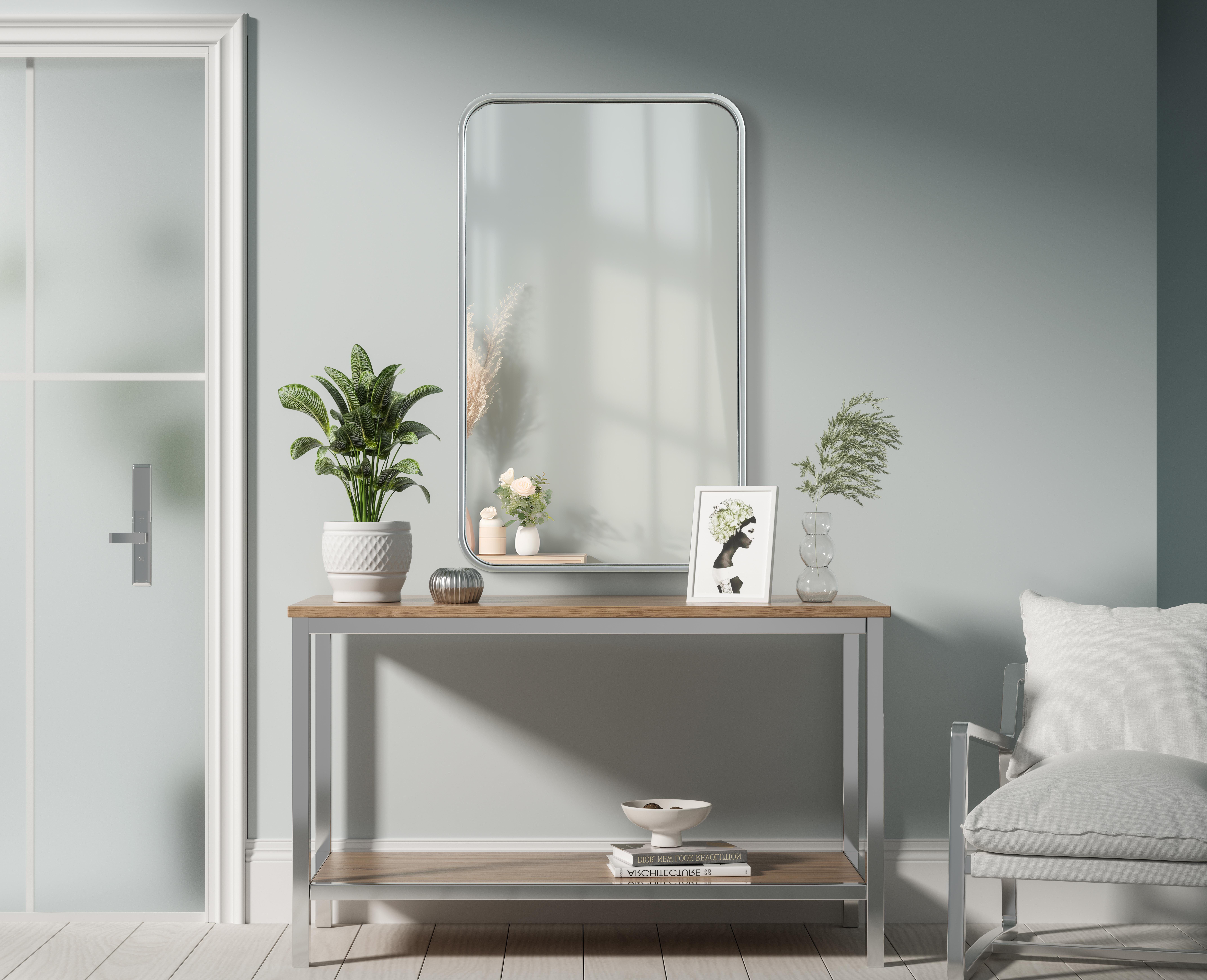 Elevate your home décor with this versatile wall mirror that combines functionality and modern design. Made from a sturdy combination of MDF, iron, and reflective mirror glass, this piece is built to last while adding a polished finish to any room. The extended depth of the frame not only provides a striking dimensional effect but also ensures the mirror's presence commands attention as a focal point. Whether you're decorating a bedroom, bathroom, or entryway, its diverse shapes—including rectangle and square—offer plenty of options to suit your style. The hand-painted black, brass, or silver finish brings a subtle yet striking touch, complemented by rounded corners for a smooth and contemporary aesthetic. With four metal inset hangers, it's ready to hang vertically or horizontally, ensuring flexibility for any layout. Available in multiple sizes, this mirror is a statement piece that blends seamlessly into both modern and classic spaces. Collection: Remy Rooms: Hallway, Living room, Bedroom, Entry Way, Office Finish: Silver Width: 18.00" Height: 30.00" Weight: 14.00 lb Extension from Wall: 2.00" Material: Iron and MDF Country of Origin: China Manufacturer Warranty: 1 year limited - alternate view