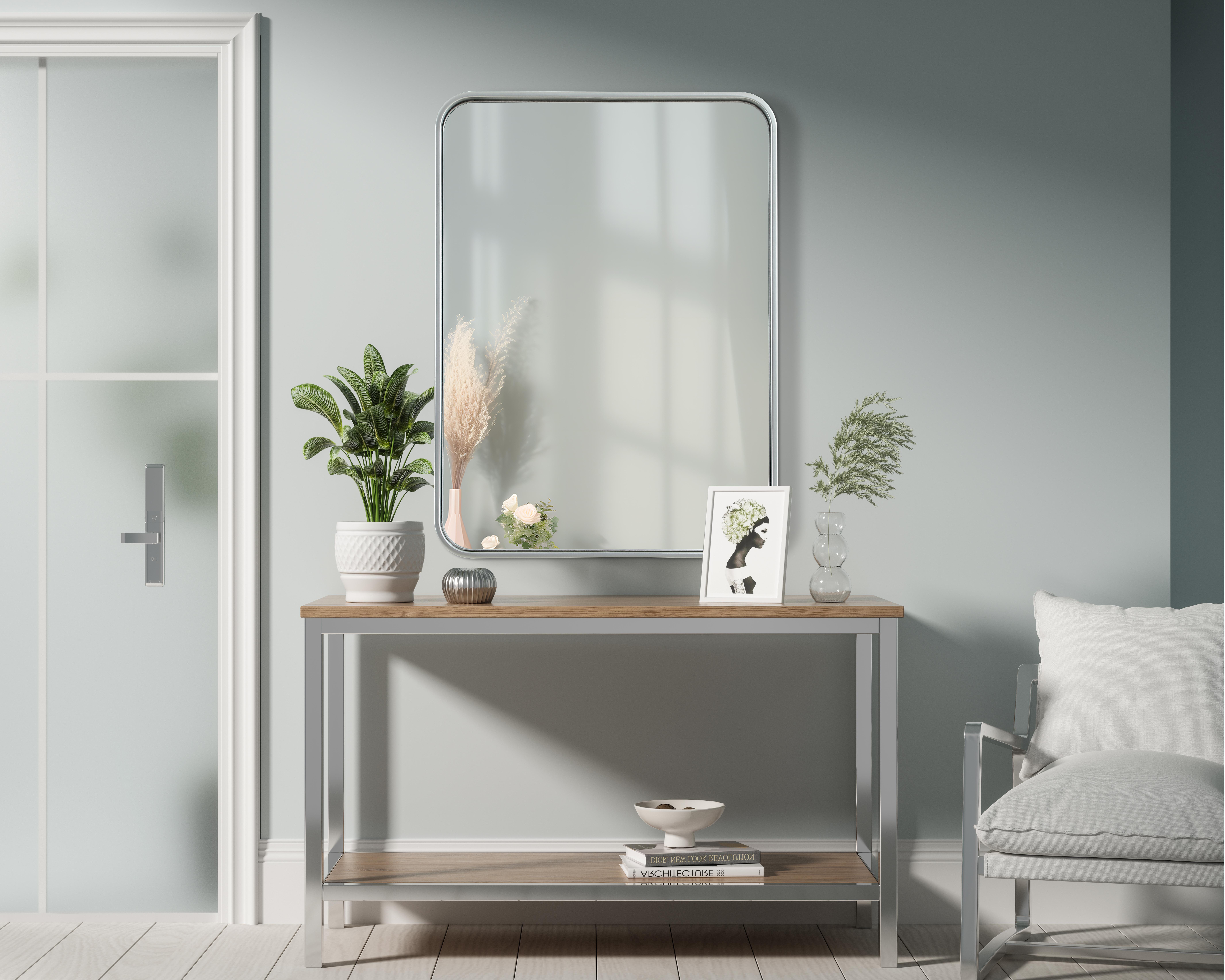 Elevate your home décor with this versatile wall mirror that combines functionality and modern design. Made from a sturdy combination of MDF, iron, and reflective mirror glass, this piece is built to last while adding a polished finish to any room. The extended depth of the frame not only provides a striking dimensional effect but also ensures the mirror's presence commands attention as a focal point. Whether you're decorating a bedroom, bathroom, or entryway, its diverse shapes—including rectangle and square—offer plenty of options to suit your style. The hand-painted black, brass, or silver finish brings a subtle yet striking touch, complemented by rounded corners for a smooth and contemporary aesthetic. With four metal inset hangers, it's ready to hang vertically or horizontally, ensuring flexibility for any layout. Available in multiple sizes, this mirror is a statement piece that blends seamlessly into both modern and classic spaces. Collection: Remy Rooms: Hallway, Living room, Bedroom, Entry Way, Office Finish: Silver Width: 22.00" Height: 30.00" Weight: 17.00 lb Extension from Wall: 2.00" Material: Iron and MDF Country of Origin: China Manufacturer Warranty: 1 year limited - alternate view
