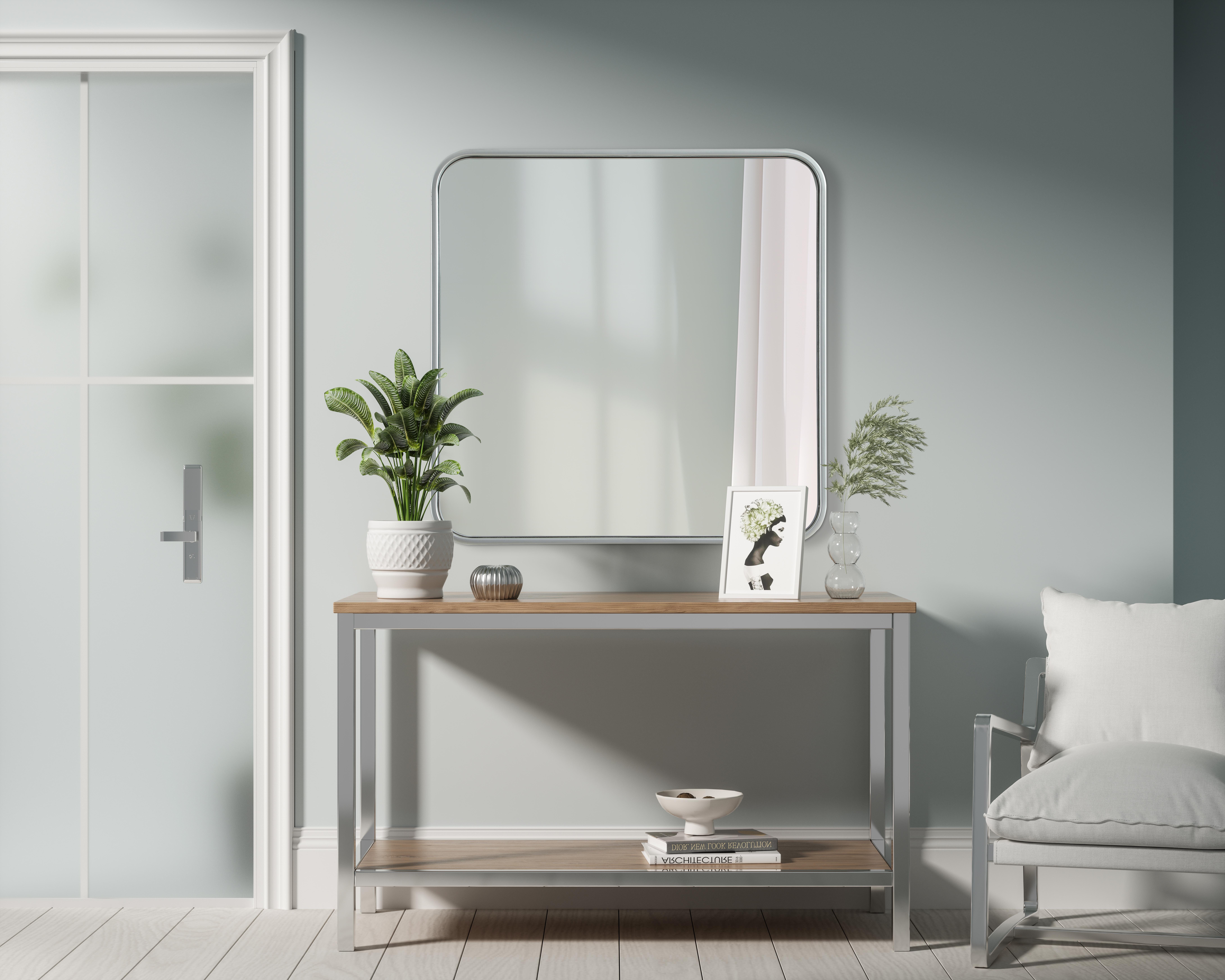 Elevate your home décor with this versatile wall mirror that combines functionality and modern design. Made from a sturdy combination of MDF, iron, and reflective mirror glass, this piece is built to last while adding a polished finish to any room. The extended depth of the frame not only provides a striking dimensional effect but also ensures the mirror's presence commands attention as a focal point. Whether you're decorating a bedroom, bathroom, or entryway, its diverse shapes—including rectangle and square—offer plenty of options to suit your style. The hand-painted black, brass, or silver finish brings a subtle yet striking touch, complemented by rounded corners for a smooth and contemporary aesthetic. With four metal inset hangers, it's ready to hang vertically or horizontally, ensuring flexibility for any layout. Available in multiple sizes, this mirror is a statement piece that blends seamlessly into both modern and classic spaces. Collection: Remy Rooms: Hallway, Living room, Bedroom, Entry Way, Office Finish: Silver Width: 24.00" Height: 24.00" Weight: 15.00 lb Extension from Wall: 2.00" Material: Iron and MDF Country of Origin: China Manufacturer Warranty: 1 year limited - alternate view