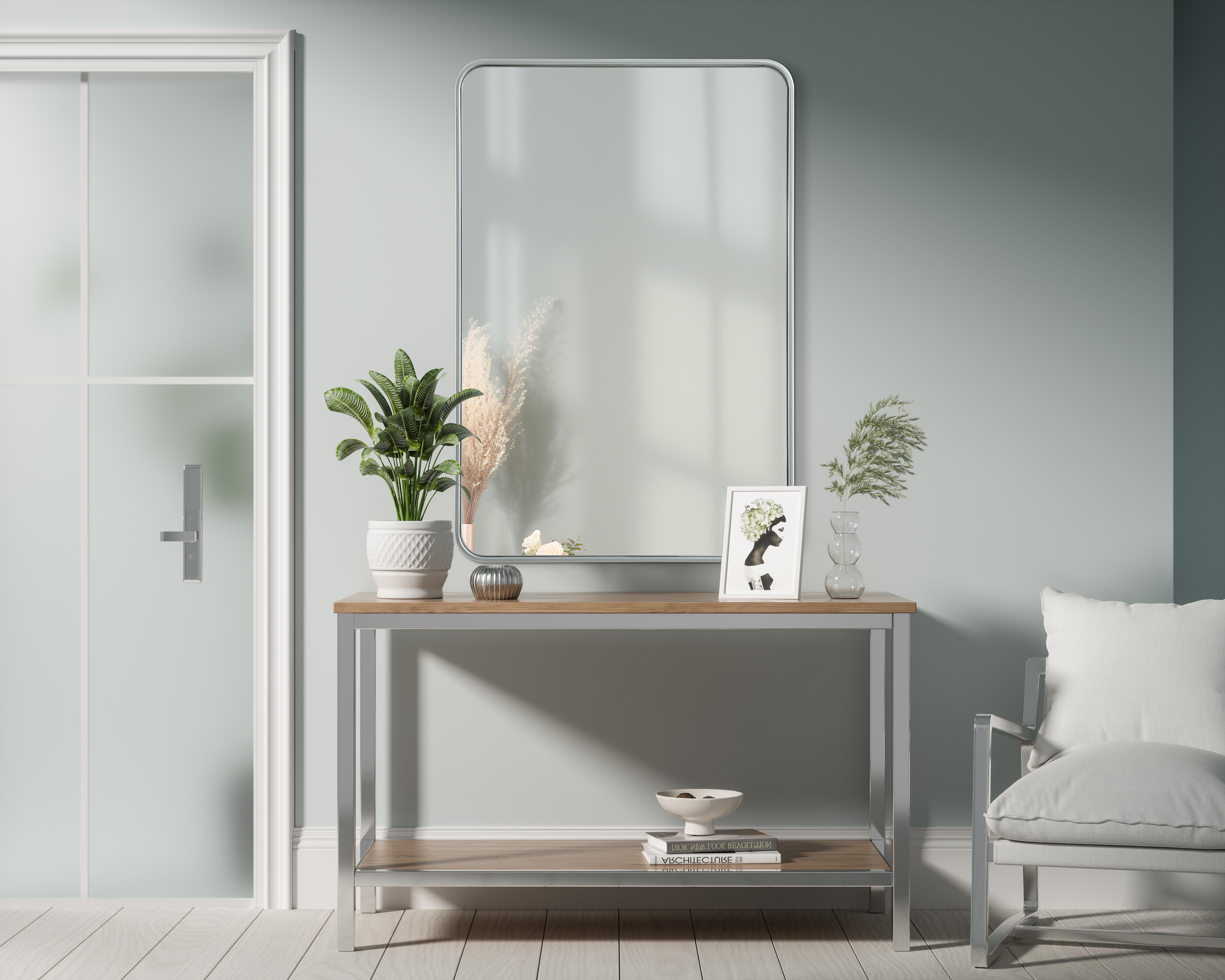Elevate your home décor with this versatile wall mirror that combines functionality and modern design. Made from a sturdy combination of MDF, iron, and reflective mirror glass, this piece is built to last while adding a polished finish to any room. The extended depth of the frame not only provides a striking dimensional effect but also ensures the mirror's presence commands attention as a focal point. Whether you're decorating a bedroom, bathroom, or entryway, its diverse shapes—including rectangle and square—offer plenty of options to suit your style. The hand-painted black, brass, or silver finish brings a subtle yet striking touch, complemented by rounded corners for a smooth and contemporary aesthetic. With four metal inset hangers, it's ready to hang vertically or horizontally, ensuring flexibility for any layout. Available in multiple sizes, this mirror is a statement piece that blends seamlessly into both modern and classic spaces. Collection: Remy Rooms: Hallway, Living room, Bedroom, Entry Way, Office Finish: Silver Width: 27.00" Height: 40.00" Weight: 26.00 lb Extension from Wall: 2.00" Material: Iron and MDF Country of Origin: China Manufacturer Warranty: 1 year limited - alternate view