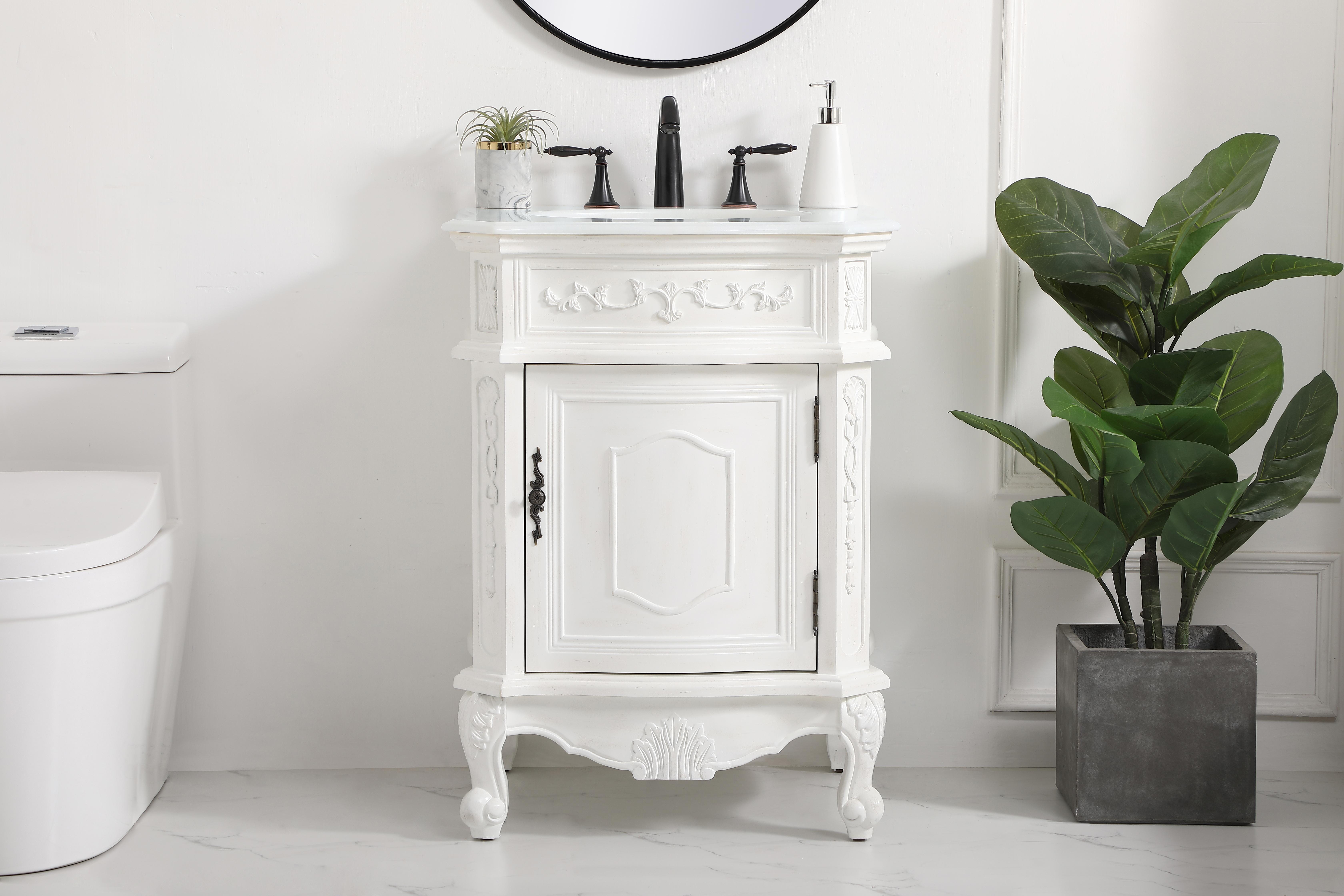 Dimensions
Length: 24"
Width: 21.75"
Height: 34"
Counter Top Length: 24"
Counter Top Width: 21.75"
Counter Top Height: 0.75"
Sink Width: 15.38"
Sink Depth: 12.38"
Sink Height: 7"
Sink Drain Hole Size: 1.75"
Faucet Hole Spacing: 8"3 Holes"
Specifications
Assembly Required: no
Base Material: Solid wood and MDF
Counter Top Edge Style: Ogee
Counter Top Finish: Ivory white
Distressed Finish: Yes
Finish (Color): Antique White
Fixture Material: Solid Wood and MDF
Hardware Finish: Antique bronze
Harware Material: Aluminum alloy
Number of Faucet Holes: 3
Number of Sinks: 1
Product Shape: Rectangle
Product Type: Bathroom Vanities
Product Warranty: 1 year limited
Sink Mounting Type: Undermount
Vanity Backsplash: NO
Vanity Mounting Type: Free-Standing
Weight: 92
Wire Included: No
Wood Type: birch
Shipment type: Oversized Ground
US Shipping Cost: $128.00
Shelves
Number of Shelves: 1
Shelf Width: 16.75
Cabinets
Number of Cabinets: 1
Cabinet Interior Width: 16.75
Cabinet Interior Depth: 16
Cabinet Interior Height: 17.75 - alternate view