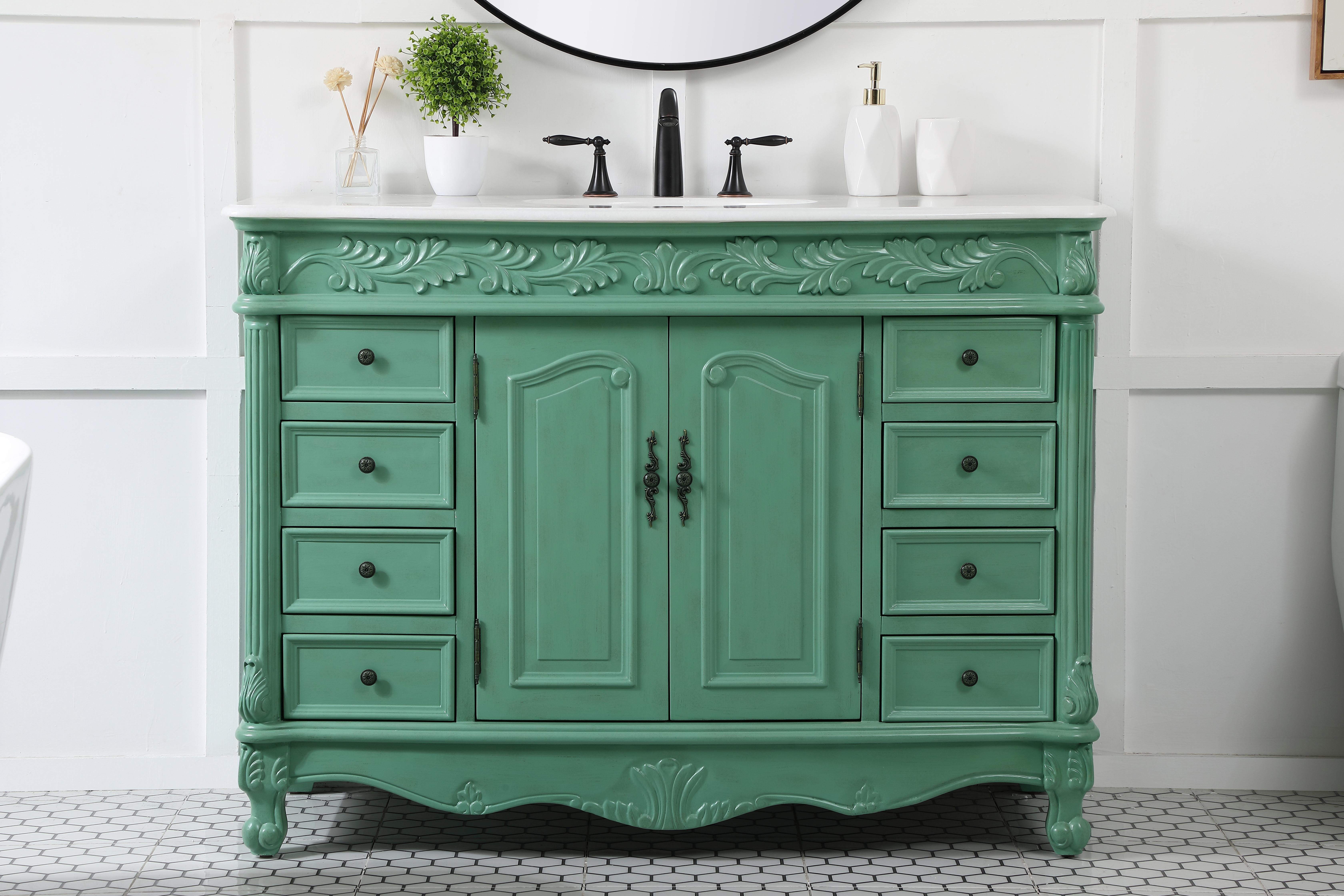 Dimensions
Length: 48"
Width: 22"
Height: 36"
Counter Top Length: 48"
Counter Top Width: 22"
Counter Top Height: 0.75"
Sink Width: 16"
Sink Depth: 13"
Sink Height: 7"
Sink Drain Hole Size: 1.75"
Faucet Hole Spacing: 8"3 Holes"
Specifications
Assembly Required: no
Base Material: Solid wood and MDF
Counter Top Edge Style: Ogee
Counter Top Finish: Ivory white
Distressed Finish: Yes
Finish (Color): Vintage Mint
Fixture Material: Solid Wood and MDF
Hardware Finish: Antique bronze
Harware Material: Aluminum alloy
Number of Faucet Holes: 3
Number of Sinks: 1
Product Shape: Rectangle
Product Type: Bathroom Vanities
Product Warranty: 1 year limited
Sink Mounting Type: Undermount
Vanity Backsplash: NO
Vanity Mounting Type: Free-Standing
Weight: 205
Wire Included: No
Wood Type: birch
Shipment type: LTL
US Shipping Cost: $218.00
Drawers
Drawers Included: yes
Number of Drawers: 8
Drawer Width: 9.5
Drawer Depth: 15.125
Drawer Height: 4.875
Drawer Handle Designs: knobs
Shelves
Number of Shelves: 1
Shelf Width: 22.25
Cabinets
Number of Cabinets: 1
Cabinet Interior Width: 22.25
Cabinet Interior Depth: 16
Cabinet Interior Height: 21.5 - alternate view