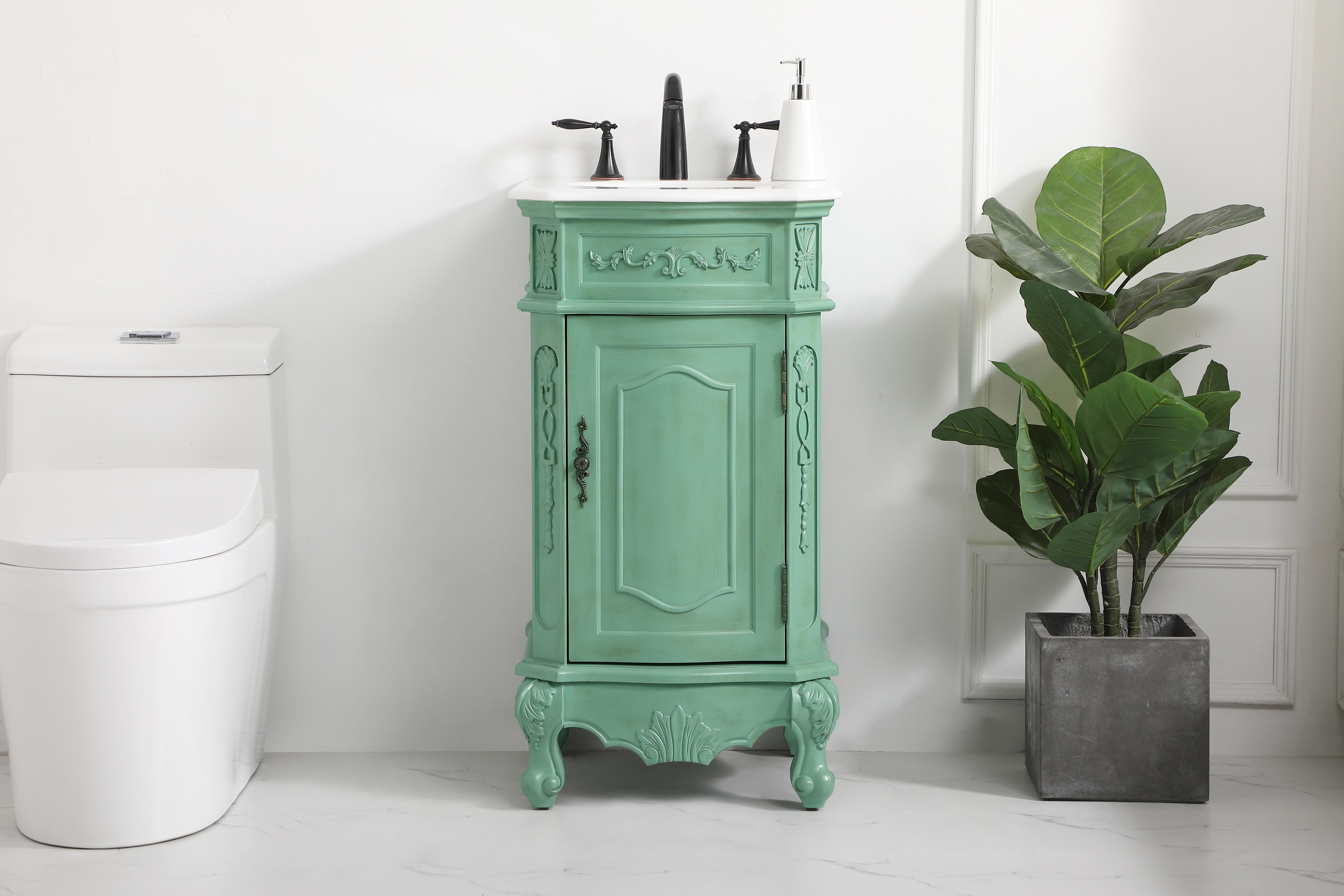 Dimensions
Length: 19"
Width: 19"
Height: 36"
Counter Top Length: 19"
Counter Top Width: 19"
Counter Top Height: 0.75"
Sink Width: 12.86"
Sink Depth: 10.86"
Sink Height: 7"
Sink Drain Hole Size: 1.75"
Faucet Hole Spacing: 8"3 Holes"
Specifications
Assembly Required: no
Base Material: Solid wood and MDF
Counter Top Edge Style: Ogee
Counter Top Finish: Ivory white
Distressed Finish: Yes
Finish (Color): Vintage Mint
Fixture Material: Solid Wood and MDF
Hardware Finish: Antique bronze
Harware Material: Aluminum alloy
Number of Faucet Holes: 3
Number of Sinks: 1
Product Shape: Rectangle
Product Type: Bathroom Vanities
Product Warranty: 1 year limited
Sink Mounting Type: Undermount
Vanity Backsplash: NO
Vanity Mounting Type: Free-Standing
Weight: 66
Wire Included: No
Wood Type: birch
Shipment type: Oversized Ground
US Shipping Cost: $118.00
Shelves
Number of Shelves: 1
Shelf Width: 12.875
Cabinets
Number of Cabinets: 1
Cabinet Interior Width: 12.875
Cabinet Interior Depth: 15.5
Cabinet Interior Height: 19.75 - alternate view