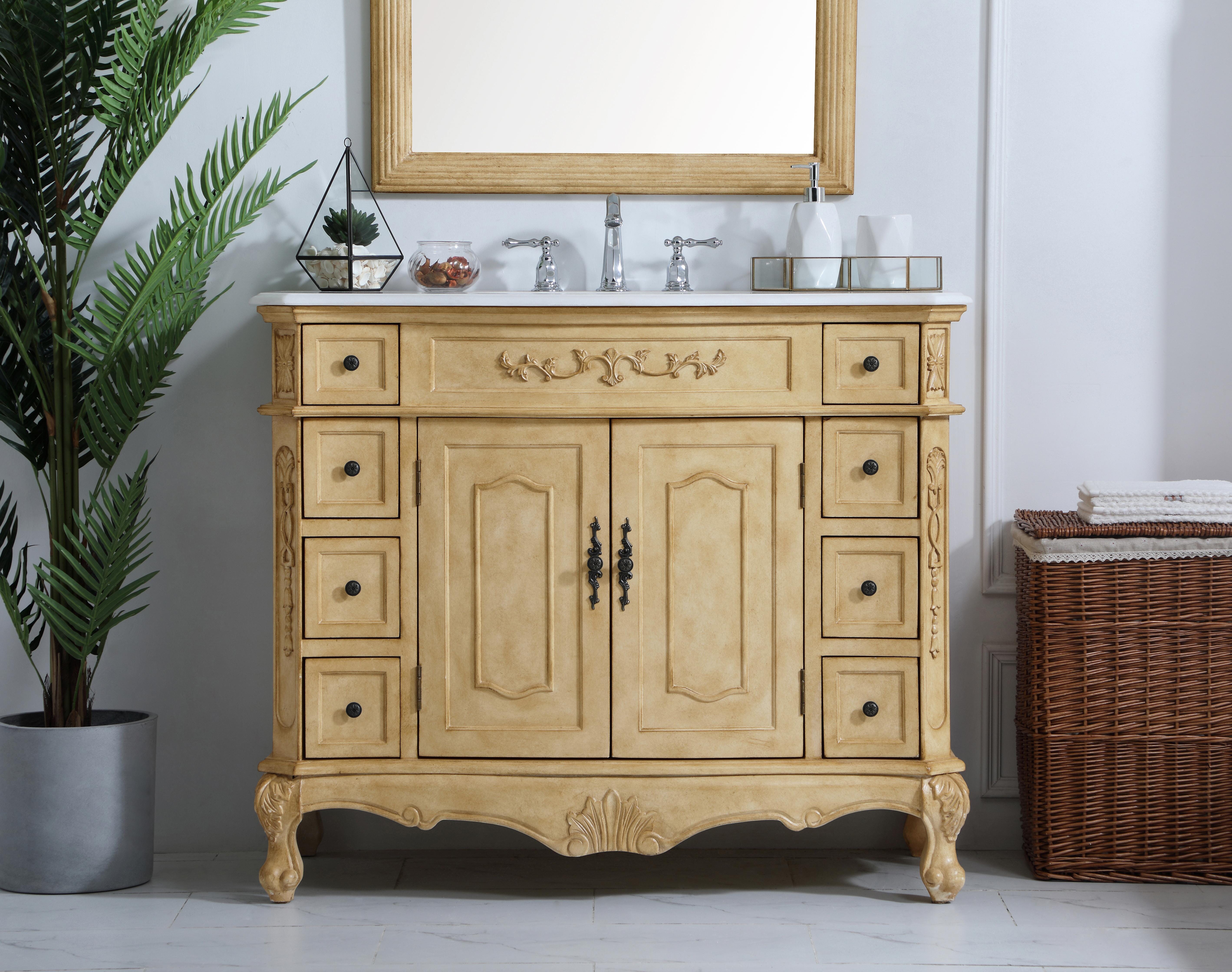Dimensions
Length: 42"
Width: 21"
Height: 36"
Counter Top Length: 42"
Counter Top Width: 21"
Counter Top Height: 0.75"
Sink Width: 16"
Sink Depth: 13"
Sink Height: 7"
Sink Drain Hole Size: 1.75"
Faucet Hole Spacing: 8"3 Holes"
Specifications
Assembly Required: no
Base Material: Solid wood and MDF
Counter Top Edge Style: Ogee
Counter Top Finish: Ivory white
Distressed Finish: Yes
Finish (Color): Antique Beige
Fixture Material: Solid Wood and MDF
Hardware Finish: Antique bronze
Harware Material: Aluminum alloy
Number of Faucet Holes: 3
Number of Sinks: 1
Product Shape: Rectangle
Product Type: Bathroom Vanities
Product Warranty: 1 year limited
Sink Mounting Type: Undermount
Vanity Backsplash: NO
Vanity Mounting Type: Free-Standing
Weight: 158
Wire Included: No
Wood Type: birch
Shipment type: LTL
US Shipping Cost: $182.00
Drawers
Drawers Included: yes
Number of Drawers: 8
Drawer Width: DW1:6
DW2:6
Drawer Depth: DW1:16
DW2:16
Drawer Height: DW1:6
DW2:4.5
Drawer Handle Designs: knobs
Shelves
Number of Shelves: 1
Shelf Width: 22
Cabinets
Number of Cabinets: 1
Cabinet Interior Width: 22
Cabinet Interior Depth: 17
Cabinet Interior Height: 19.75 - alternate view