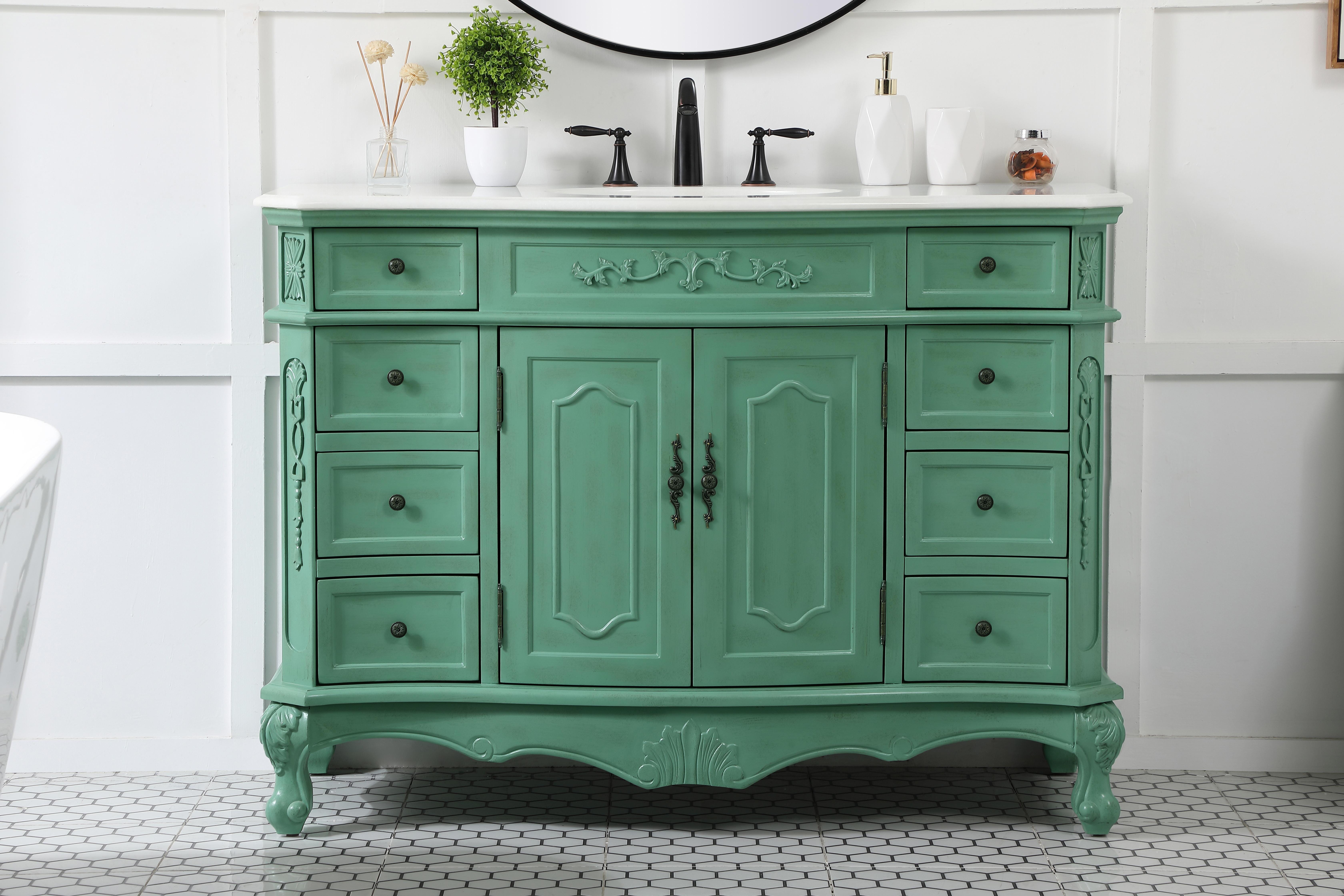 Dimensions
Length: 48"
Width: 21"
Height: 36"
Counter Top Length: 48"
Counter Top Width: 21"
Counter Top Height: 0.75"
Sink Width: 16"
Sink Depth: 13"
Sink Height: 7"
Sink Drain Hole Size: 1.75"
Faucet Hole Spacing: 8"3 Holes"
Specifications
Assembly Required: no
Base Material: Solid wood and MDF
Counter Top Edge Style: Ogee
Counter Top Finish: Ivory white
Distressed Finish: Yes
Finish (Color): Vintage Mint
Fixture Material: Solid Wood and MDF
Hardware Finish: Antique bronze
Harware Material: Aluminum alloy
Number of Faucet Holes: 3
Number of Sinks: 1
Product Shape: Rectangle
Product Type: Bathroom Vanities
Product Warranty: 1 year limited
Sink Mounting Type: Undermount
Vanity Backsplash: NO
Vanity Mounting Type: Free-Standing
Weight: 174
Wire Included: No
Wood Type: birch
Shipment type: LTL
US Shipping Cost: $206.00
Drawers
Drawers Included: yes
Number of Drawers: 8
Drawer Width: DW1:8.875
DW2:8.875
Drawer Depth: DW1:16
DW2:16
Drawer Height: DW1:4.375
DW2: 6
Drawer Handle Designs: knobs
Shelves
Number of Shelves: 1
Shelf Width: 21.75
Cabinets
Number of Cabinets: 1
Cabinet Interior Width: 21.75
Cabinet Interior Depth: 17
Cabinet Interior Height: 19.75 - alternate view
