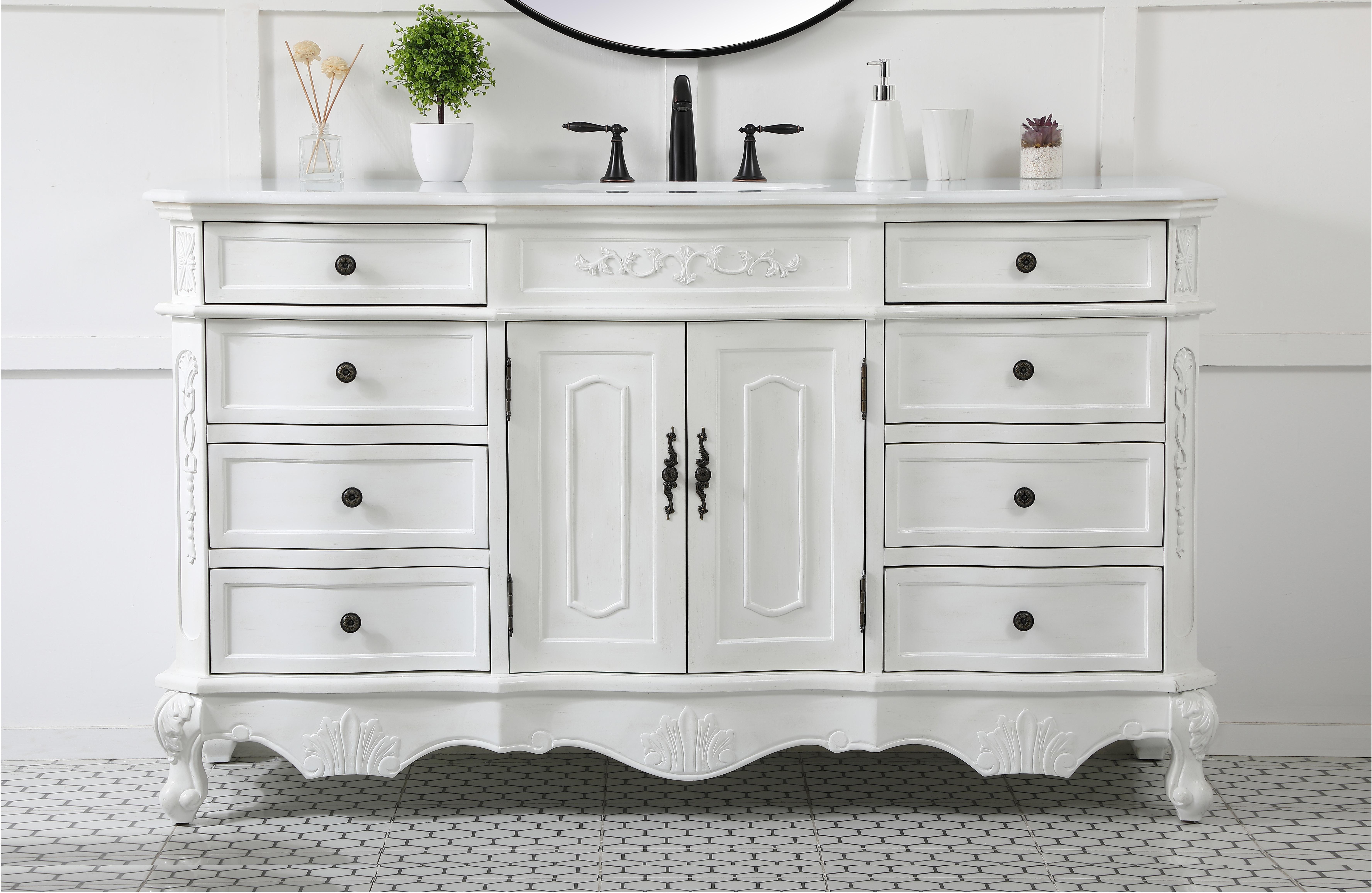 Dimensions
Length: 60"
Width: 21"
Height: 36"
Counter Top Length: 60"
Counter Top Width: 21"
Counter Top Height: 0.75"
Sink Width: 16"
Sink Depth: 13"
Sink Height: 7"
Sink Drain Hole Size: 1.75"
Faucet Hole Spacing: 8"3 Holes"
Specifications
Assembly Required: no
Base Material: Solid wood and MDF
Counter Top Edge Style: Ogee
Counter Top Finish: Ivory white
Distressed Finish: Yes
Finish (Color): Antique White
Fixture Material: Solid Wood and MDF
Hardware Finish: Antique bronze
Harware Material: Aluminum alloy
Number of Faucet Holes: 3
Number of Sinks: 1
Product Shape: Rectangle
Product Type: Bathroom Vanities
Product Warranty: 1 year limited
Sink Mounting Type: Undermount
Vanity Backsplash: NO
Vanity Mounting Type: Free-Standing
Weight: 213
Wire Included: No
Wood Type: birch
Shipment type: LTL
US Shipping Cost: $253.00
Drawers
Drawers Included: yes
Number of Drawers: 8
Drawer Width: DW1:15.75
DW2:15.75
Drawer Depth: DW1:16
DW2:16
Drawer Height: DW1:6
DW1:4.5
Drawer Handle Designs: knobs
Shelves
Number of Shelves: 1
Shelf Width: 22.875
Cabinets
Number of Cabinets: 1
Cabinet Interior Width: 22.875
Cabinet Interior Depth: 17
Cabinet Interior Height: 19.75 - alternate view