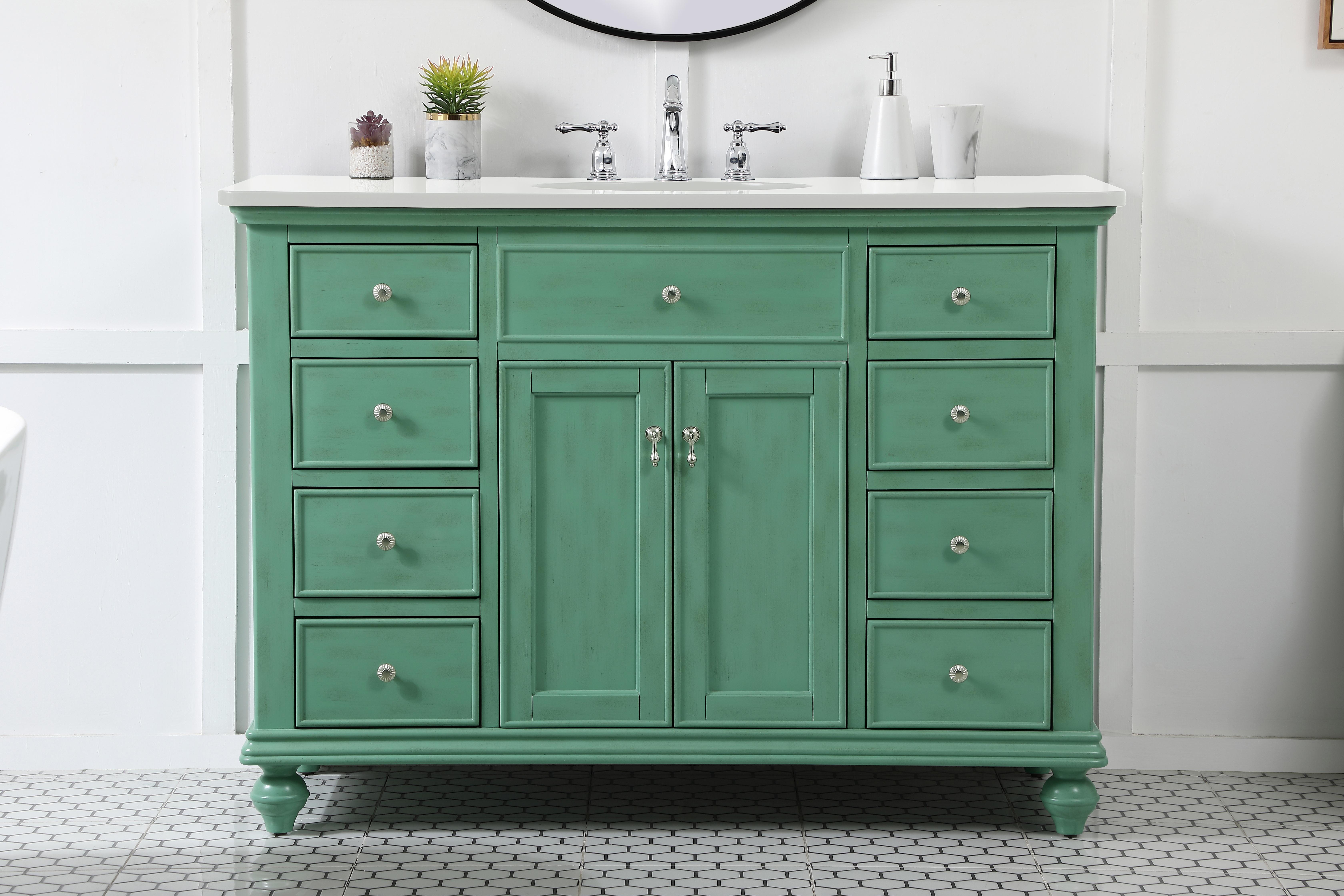 Dimensions
Length: 48"
Width: 21"
Height: 35"
Counter Top Length: 48"
Counter Top Width: 21"
Counter Top Height: 0.75"
Sink Width: 15.38"
Sink Depth: 12.25"
Sink Height: 7"
Sink Drain Hole Size: 1.75"
Faucet Hole Spacing: 8"3 Holes"
Specifications
Assembly Required: YES
Base Material: Solid wood and MDF
Counter Top Edge Style: straight
Counter Top Finish: Ivory white
Distressed Finish: Yes
Finish (Color): Vintage Mint
Fixture Material: Solid Wood and MDF
Hardware Finish: Brushed nickel
Harware Material: Aluminum alloy
Number of Faucet Holes: 3
Number of Sinks: 1
Product Shape: Rectangle
Product Type: Bathroom Vanities
Product Warranty: 1 year limited
Sink Mounting Type: Undermount
Vanity Backsplash: NO
Vanity Mounting Type: Free-Standing
Weight: 198
Wire Included: No
Wood Type: birch
Shipment type: LTL
US Shipping Cost: $196.00
Drawers
Drawers Included: yes
Number of Drawers: 8
False Drawers: yes
Drawer Width: Dw1:10 Dw2:10
Drawer Depth: Dw1:14.25 Dw2:14.25
Drawer Height: Dw1:5.13 Dw2: 6
Drawer Handle Designs: knobs
Shelves
Number of Shelves: 1
Shelf Width: 19
Cabinets
Number of Cabinets: 1
Cabinet Interior Width: 19
Cabinet Interior Depth: 18.125
Cabinet Interior Height: 20.125 - alternate view